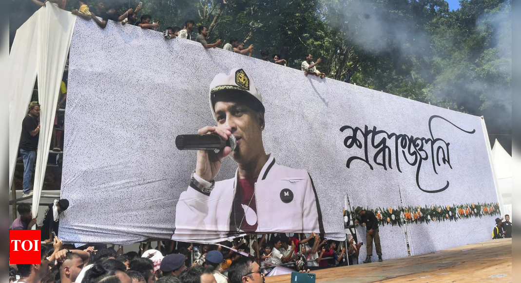People look from atop a banner during the funeral of singer Zubeen Garg, on the outskirts of Guwahati. Zubeen Garg died while scuba diving in Singapore. (PTI Photo) NEW DELHI: A month after the death of Assamese singer Zubeen Garg in Singapore, the Singapore Police Force (SPF) has said that it does not suspect any “foul play” in the case, while confirming that the investigation is ongoing.Garg, 52, died on September 19 from drowning while swimming off St John’s Island in Singapore. He was visiting the city-state as a cultural brand ambassador for the North East India Festival, which was scheduled for September 20–21.Assam Police Slaps Murder Charge On Zubeen Garg’s Manager & Festival Organiser In a statement released on Friday, the SPF urged the public not to circulate unverified information regarding the singer’s death.“The Singapore Police Force (SPF) is aware of speculation and false Information circulating online regarding the circumstances of Mr Zubeen Garg’s death. The case is currently being investigated by the SPF, in accordance with Singapore’s Coroners Act 2010. Based on preliminary investigations, the SPF does not suspect foul play,” the SPF said.The SPF added that the investigation “may take up to another three months or so” to complete. The findings will then be submitted to the “State Coroner” for a “Coroner’s Inquiry.”On October 1, 2025, the SPF shared a copy of the autopsy report and preliminary findings with the High Commission of India.”Despite the fact that SPF is still in the midst of its investigations, on 1 October 2025, it extended a copy of the autopsy report of the late Mr Garg, and SPF’s preliminary findings, to the High Commission of India upon their request,” the statement said.Meanwhile, Assam Police’s Special Investigation Team (SIT) has arrested seven people in connection with Garg’s death since October 1. All of them have been remanded to judicial custody.About the AuthorTOI News DeskThe TOI News Desk comprises a dedicated and tireless team of journalists who operate around the clock to deliver the most current and comprehensive news and updates to the readers of The Times of India worldwide. With an unwavering commitment to excellence in journalism, our team is at the forefront of gathering, verifying, and presenting breaking news, in-depth analysis, and insightful reports on a wide range of topics. The TOI News Desk is your trusted source for staying informed and connected to the ever-evolving global landscape, ensuring that our readers are equipped with the latest developments that matter most.”Read MoreEnd of ArticleFollow Us On Social MediaVideosBelgian Court Clears Fugitive Jeweller Mehul Choksi’s Extradition To IndiaPortfolios Allocated To Gujarat’s New Ministers After Major Cabinet ReshufflePakistan Seeks Trump’s Intervention After Afghan-Taliban Forces Humiliate Pak Army In Border ClashDense Chhattisgarh Forests No Longer Safe For Naxals, Over 200 Maoists Lay Down ArmsChina Breaks Silence on Border Clash, Follows India To Tell Pakistan, Afghanistan to End CrisisPakistan-Afghanistan Border Tensions Explode Ahead Of Ceasefire Deadline: Blast Kills 7 Pak Soldiers‘Jungle Raj’: Amit Shah Slams RJD For Fielding Shahabuddin’s Son In Bihar ElectionsAir Power, Tech Will Define Future Wars: Defence Secretary Rajesh Singh at Tejas Mk1A Showcase EventHAL Celebrates Maiden Flight of the First Tejas Mk1A Fighter Jet Manufactured at its Nashik FacilityRahul Gandhi Meets Family of Lynched Dalit in UP, Claims Govt Threatened Them and Calls for Action123 Photostories  Dhanteras 2025: 5 best AI prompts to generate gold jewellery looks for the festive seasonHindi parallel cinema gems that reshaped storytelling with power, purpose and heart7 types of rotis, their digestion time, and the right weather to eat6 essential skills you need to outsmart AI and stay ahead in the future of workMorning-after rescue: Natural remedies to recover from Diwali drinksDhanteras 2025: 5 minimal gold ring designs perfect for daily wear10 mind-blowing superpowers of chameleonsFrom Archana Puran Singh’s nostalgic Dehradun Diwali to fun housie nights with staff – Archana and Parmeet Sethi’s cherished family Diwali memories3 superfoods to control cholesterol and the right way to consume them6 ways to set healthy boundaries without pushing others away123Hot PicksGold Silver PriceRiyadh AirBihar Election 2025Gold rate todaySilver rate todayPublic Holidays OctoberBank Holidays OctoberTop TrendingCardi BCarson WentzTrevon DiggsJustin HerbertStephen CurryJoel EmbiidLeBron JamesCarolina HurricanesLeon DraisaitlStephanie Lachances