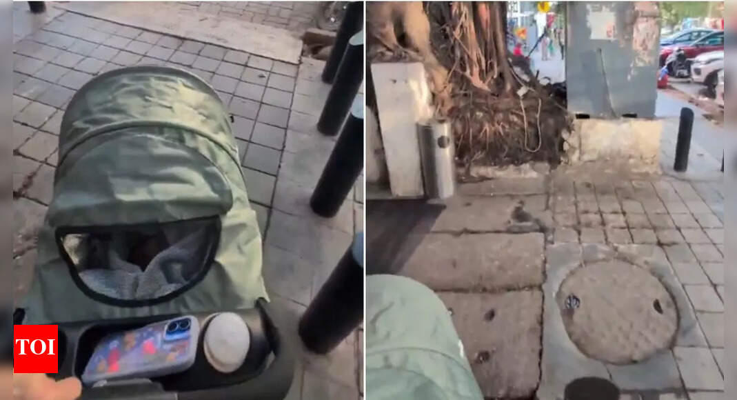 A viral video shows the difficulties of walking on Indian footpaths. Content creator Caleb Friesen struggled with a baby stroller in Bengaluru, encountering numerous obstructions. His post humorously ranked these obstacles, placing pedestrians last. The video has sparked conversations about footpath accessibility across Indian cities. Friesen aims to raise awareness about these issues. Screengrab from viral video (Image/X)  NEW DELHI: A video showing the challenges of walking on Indian footpaths, especially for parents and pedestrians, has gone viral on social media. The 32-second clip, posted on Thursday by Canadian content creator and podcaster Caleb Friesen, shows him navigating a baby stroller along a footpath and highlighted the reality of being a pedestrian parent in India.In the video, Friesen struggles to manoeuvre the stroller around obstacles including electrical poles, power junction boxes and other common footpath obstructions. Shots Fired At Kapil Sharma’s Cafe In Canada For Third Time; Bishnoi Gang Claims ResponsibilitySharing the video on X, he sarcastically listed the “descending order of importance” for things found on Indian footpaths, placing pedestrians and parents with strollers at the bottom. The list goes as: Power junction boxesElectrical polesHoardingsFood stallsDarshini overflowParked vehiclesTreesPotted plantsPedestriansParents with strollers/differently-abled in wheelchairsFriesen confirmed that the location was a footpath on 100 Feet Road in Bangalore. Explaining the issue further, he told one user that the problem was not the bollards, which prevent two-wheelers from entering the footpath, but the massive power junction boxes occupying half the space.The post has drawn widespread attention, garnering over 230K views. Many users empathised with Friesen’s experience, sharing their own struggles navigating uneven or blocked footpaths in Indian cities.One user wrote, “It’s brave of you to do this experiment. Last week in Pune, my father tried to roll a suitcase on the footpath and slipped because it got stuck in a pothole. Tier-1 cities don’t even provide a seamless 100m path.” Another user cautioned him, “For your kid’s safety, please avoid walking on the footpath. Better safe than sorry.”This is not Friesen’s first post highlighting footpath hazards. Last month, he shared a video of his 2.4 km walk from Majestic bus stand to a nearby Starbucks, pointing out obstacles such as tunnel juice, barbed wire, desire paths, bushwhacking, pavement pudding and a stairwell into a drain.Despite his wry commentary, he emphasised that his intention is not to criticise India but to raise awareness. He said: “I don’t just want to criticise India, I care deeply about this country.”About the AuthorTOI News DeskThe TOI News Desk comprises a dedicated and tireless team of journalists who operate around the clock to deliver the most current and comprehensive news and updates to the readers of The Times of India worldwide. With an unwavering commitment to excellence in journalism, our team is at the forefront of gathering, verifying, and presenting breaking news, in-depth analysis, and insightful reports on a wide range of topics. The TOI News Desk is your trusted source for staying informed and connected to the ever-evolving global landscape, ensuring that our readers are equipped with the latest developments that matter most.”Read MoreEnd of ArticleFollow Us On Social MediaVideosTrump Doubles Down on Russian Oil Bluff Despite MEA Fact-Check, Repeats India-Pak Ceasefire ClaimPak-Afghan Border Clash: Airstrike Kills 3 Afghan Cricketers, ACB and Rashid Khan Blast IslamabadBelgian Court Clears Fugitive Jeweller Mehul Choksi’s Extradition To IndiaPortfolios Allocated To Gujarat’s New Ministers After Major Cabinet ReshufflePakistan Seeks Trump’s Intervention After Afghan-Taliban Forces Humiliate Pak Army In Border ClashDense Chhattisgarh Forests No Longer Safe For Naxals, Over 200 Maoists Lay Down ArmsChina Breaks Silence on Border Clash, Follows India To Tell Pakistan, Afghanistan to End CrisisPakistan-Afghanistan Border Tensions Explode Ahead Of Ceasefire Deadline: Blast Kills 7 Pak Soldiers‘Jungle Raj’: Amit Shah Slams RJD For Fielding Shahabuddin’s Son In Bihar ElectionsAir Power, Tech Will Define Future Wars: Defence Secretary Rajesh Singh at Tejas Mk1A Showcase Event123 Photostories  5 signs you’re growing apart in your marriage– and how to reconnect with your partnerHow Shah Rukh Khan turned grey roles into iconic characters with charm and depthDiwali 2025: Bollywood characters inspired looks to try this festival4 essential rituals to follow during Kartik monthYour posture may reveal hidden stress: Here’s which posture is the most dangerousIs chandi ka warq or silver leaf on sweets made from animal parts?10 countries where the Indian rupee is stronger and luxury isn’t out of reach9 traditional South Indian dosas to enjoy for breakfast6 colourful animals that look straight out of a rainbowDhanteras 2025: 5 best AI prompts to generate gold jewellery looks for the festive season123Hot PicksGold Silver PriceRiyadh AirBihar Election 2025Gold rate todaySilver rate todayPublic Holidays OctoberBank Holidays OctoberTop TrendingCardi BMega Lucario and Riolu Early in PokemonAdam SandlerCharlotte Hornets vs New York KnicksCardi B PregnancyBad BunnyDuke RoufusCarolina HurricanesLeon DraisaitlStephanie Lachances