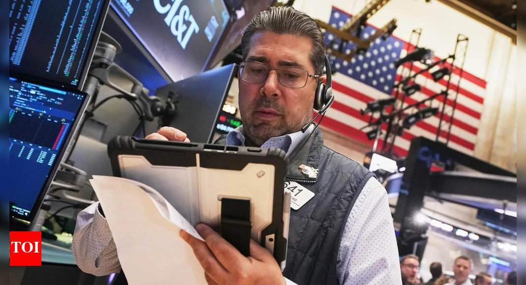 US stocks today: Wall Street holds near record highs as investors await Tesla earnings; Gold slips again