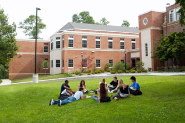 Which college is signing Trump’s compact?