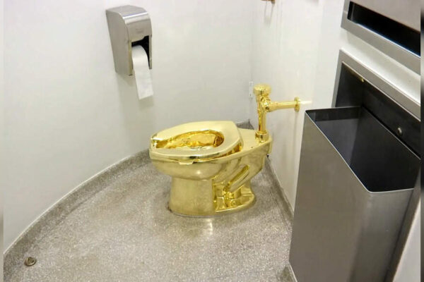 A solid gold toilet is up for auction. Starting price:  million