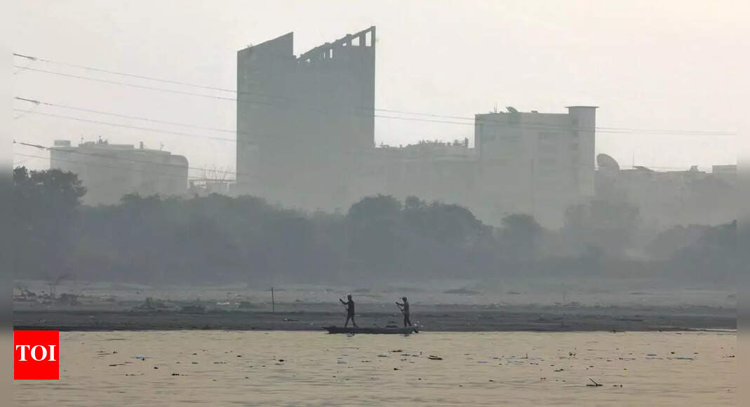 Delhi ranked sixth most polluted city in India in October, with PM2.5 levels nearly tripling from September. A CREA report highlighted a sharp air quality drop across the Indo-Gangetic Plain, with Dharuhera in Haryana topping the list. The findings underscore the impact of year-round pollution sources beyond seasonal factors. Smog blankets the Yamuna in Delhi (PTI file photo) NEW DELHI: Delhi was ranked the sixth most polluted city in India in October, trailing behind Ghaziabad and Noida, according to a new report by the Centre for Research on Energy and Clean Air (CREA).The study, based on continuous air quality monitoring data, found a sharp drop in air quality across the Indo-Gangetic Plain, particularly in the National Capital Region. Dharuhera in Haryana topped the list as the most polluted city, recording a monthly average PM2.5 level of 123 µg/m³, double the national safe limit.Delhi’s air quality also worsened significantly, with its monthly average rising to 107 µg/m³, nearly three times higher than in September. CREA noted that while stubble burning contributed less than six per cent of Delhi’s PM2.5 levels in October, the spike points to the impact of year-round pollution sources and the limits of short-term seasonal measures like the Graded Response Action Plan.Dharuhera breached national air quality standards on 77 per cent of the days last month, logging two ‘severe’ and nine ‘very poor’ days. Other cities high on the pollution list included Rohtak, Ghaziabad, Noida, Ballabgarh, Bhiwadi, Greater Noida, Hapur, and Gurgaon, most of them part of the NCR region.Top 10 most polluted cities Dharuhera, HaryanaRohtak, HaryanaGhaziabad, Uttar PradeshNoida, Uttar PradeshBallabgarh, HaryanaDelhi, National Capital TerritoryBhiwadi, RajasthanGreater Noida, Uttar PradeshHapur, Uttar PradeshGurgaon, HaryanaAlso read: Data under fire, SC seeks report on measures to tackle pollutionAt the other end, Shillong in Meghalaya was India’s cleanest city, with an average PM2.5 concentration of 10 µg/m³. Four cities from Karnataka and three from Tamil Nadu also featured among the top 10 cleanest.Out of 249 cities analysed, 212 met India’s national air quality standards, but only six complied with the World Health Organisation’s safe limit of 15 µg/m³. The report also showed a sharp decline in the number of cities with ‘good’ air quality, dropping from 179 in September to just 68 in October.About the AuthorTOI News DeskThe TOI News Desk comprises a dedicated and tireless team of journalists who operate around the clock to deliver the most current and comprehensive news and updates to the readers of The Times of India worldwide. With an unwavering commitment to excellence in journalism, our team is at the forefront of gathering, verifying, and presenting breaking news, in-depth analysis, and insightful reports on a wide range of topics. The TOI News Desk is your trusted source for staying informed and connected to the ever-evolving global landscape, ensuring that our readers are equipped with the latest developments that matter most.”Read MoreEnd of ArticleFollow Us On Social MediaVideosWill Nitish Kumar’s ‘Jeevika Didi’ Scheme Sway Women Voters? Ground Report From Bihar’s Korha’Days Of Maoists Are Numbered In India’: Bastar Top Cop Issues Final Warning To Left Wing Extremists‘India Is The Future’: Israel FM Backs Delhi’s Rise, Eyes Deeper Strategic And Security Ties NowFatal US Crash: Sober Indian-Origin Driver Charged With Homicide, Linked To Border Policy DebateCanada Rejects 74% Indian Student Visas In August, Citing Fraud, As Ties With India Hit New LowJaishankar, Israeli FM Forge New Security Front, Call Radical Terror A Mutual Threat To Both NationsHorror In Coimbatore: Student Gang Raped After Abduction, Three Accused Shot And Arrested By Police’Will Cut Off Your Tongue’: Bihar Poll Campaign Turns Ugly, AIMIM Candidate Threatens Tejashwi YadavUS Courts Halt Deportation Of Indian-Origin Man Wrongfully Jailed For 43 Years In False Murder CaseCongress vs Congress: Tharoor’s Essay Triggers Storm, BJP Adds Fuel With Jibe123 Photostories  People who live the longest have these 10 things in common: Most of them might surprise youJennifer Lopez to Yami Gautam: 5 best celebrity looks of the dayHow to grow blueberries in your balcony garden; step by step tips7 reasons to have a bowl of papaya with lemon for breakfastSara Ali Khan, Shraddha Kapoor to Mouni Roy: Bollywood stars visiting temples and spiritual spotsBengaluru’s Big Rail Makeover: 3 Stations to Get Modern Holding Areas; KSR, SMVT and KR Puram to have modular zones for 7,000 passengers, promising smoother and more comfortable travel by next yearHyderabad welcomes Netflix’s new global centre: After Mumbai, the streaming major picks HITEC City for its 40,000 sq ft tech and VFX hub; another milestone in the city’s rise as a creative powerhouseChennai’s Tambaram gears up for monsoon with Rs 12-crore drain upgrade New stormwater network, concrete culverts, and road revamps take shape A city’s bold bid to end years of flooding and stagnation woesBengaluru’s Rs 17,698 crore tunnel road plan: Mega fix or mega gamble for a city choking on its own growth?World’s top 10 most capitalist countries that make great travel destinations too123Hot PicksStock market holidayBank HolidayBihar Election 2025Gold rate todaySilver rate todayPublic Holidays NovemberBank Holidays NovemberTop TrendingTaylor SwiftJalen Green GirlfriendKyle KulinskiWilliam NylanderMLB Trade RumorsTravis Kelce InjuryPaige SpiranacBlake TreinenTyrese Haliburton InjuryBengaluru Scooter Accident