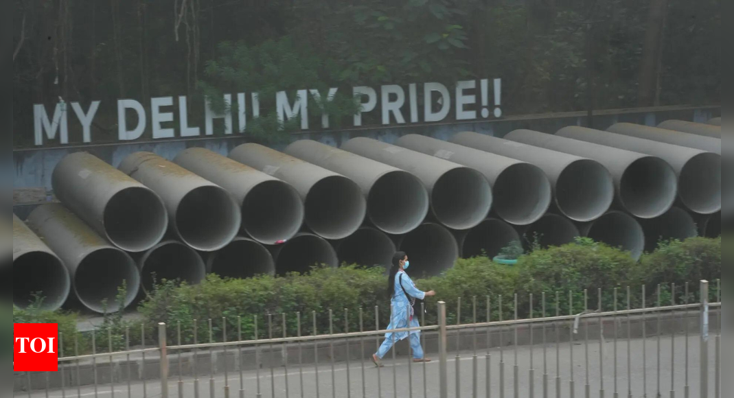 Delhi’s air quality has entered the ‘red zone’ with AQI crossing 400, making it the country’s second most polluted city. Despite hazardous levels in several areas, Graded Response Action Plan (GRAP) Stage 3 has not been enforced due to comparatively better air quality this November than last year, attributed to coordinated pollution control measures. Image credit: AP NEW DELHI: The national capital on Saturday entered the “red zone” after the air quality index (AQI) crossed 400-mark, making the situation adverse for Delhiites and the citizens in the national capital region.With a 24-hour average AQI of 361, Delhi became the country’s second most polluted city, according to CPCB data. Several areas, including Wazirpur (420), Burari (418), and Vivek Vihar (411), recorded “severe” pollution levels, while most others hovered in the ‘very poor’ range. In the NCR, Noida (354), Greater Noida (336), and Ghaziabad (339) also reported hazardous air, underscoring the region’s worsening smog crisis.The air quality early warning system for Delhi has forecast that the city’s air will stay in the ‘very poor’ category for the coming days. Since Diwali, the capital’s air quality has largely hovered between ‘poor’ and ‘very poor’, at times deteriorating to ‘severe’ levels.Why GRAP 3 not yet enforced?Graded Response Action Plan (GRAP) stage 3 has not been enforced yet because, according to the Delhi Pollution Control Committee (DPCC), the city’s air quality this November has remained comparatively better than the same period last year. Officials said that pollution levels have not yet reached the severe threshold that would trigger Stage 3 restrictions. They credited this improvement to timely and coordinated actions across departments, including intensified dust control, road cleaning, anti-smog operations, and stricter checks on vehicles and industrial emissions, which have helped delay the need for harsher measures.”Out of the last seven days, six have recorded better air quality than the corresponding days last year. This has been possible because of timely and coordinated action taken across departments,” PTI quoted an official saying.”Last year, GRAP Stage 3 was imposed on November 13. This time, with support from all departments and the residents of Delhi, we hope to prevent reaching that stage,” the official said.About the AuthorTOI News DeskThe TOI News Desk comprises a dedicated and tireless team of journalists who operate around the clock to deliver the most current and comprehensive news and updates to the readers of The Times of India worldwide. With an unwavering commitment to excellence in journalism, our team is at the forefront of gathering, verifying, and presenting breaking news, in-depth analysis, and insightful reports on a wide range of topics. The TOI News Desk is your trusted source for staying informed and connected to the ever-evolving global landscape, ensuring that our readers are equipped with the latest developments that matter most.”Read MoreEnd of ArticleFollow Us On Social MediaVideos‘Bulldozer Will Roll Over Corruption’: Yogi Adityanath’s Fierce Attack on RJD-Congress’Modi Runs Empire Of Fear, We’re Fighting Mahatma’s Battle’: Priyanka Gandhi Targets PM In BiharDeadlock Deepens: Afghanistan Calls Pakistan Irresponsible As Peace Talks Break Down Once AgainPM Modi’s ‘65-Volt Jhatka’ Jibe Rocks Bihar Rally, Mocks Rahul’s Pond Dive As ‘Doobne Ki Practice’From Canada To New Zealand, The World Sings Along As India’s National Song ‘Vande Mataram’ Turns 150CIA Whistleblower Confirms Pakistan’s F-16s Were Nuke-Capable, But US Hid The Truth From The WorldBangladesh: NCP Warns Of Political Violence Ahead Of First Polls Since Ex-PM Sheikh Hasina’s Ouster‘They Were Treated Badly’: Families of Indians Trapped in Myanmar Job Scam React, MEA Sounds WarningPM Modi Flags Off Four Vande Bharat Express Trains From Varanasi, Says ‘New India On Fast Track’Massive Fire Engulf Bengali Basti Near Rithala Metro, One Killed As Firefighters Battle Flames123PhotostoriesFrom ‘Lakdi Ki Kaathi’ to ‘Chanda Hai Tu’: Bollywood songs that still keep the child in you aliveFrom Hrithik Roshan to Alia Bhatt: Meet child actors who became stars in Bollywood3 Ayurveda-approved steam blends for blocked nose and scratchy throatBigg Boss Malayalam 7: Here’s everything about the top 5 finalists of the seasonBigg Boss 19: From an Age Gap of 9 Years to Their Love Story- All About Gaurav Khanna’s Wife Akanksha Chamola and Their RelationshipFrom ‘Delhi Crime Season 3’ to ‘Jurassic World Rebirth’: Upcoming week’s OTT releases12 deep-fried foods to enjoy with chai during the winter season10 flowers that mostly bloom in November‘English Vinglish’,‘Dil Dhadakne Do’ to ‘Kapoor & Sons’: When Bollywood broke the sanskaari mold and portrayed families as they really areAnanya Panday to Ariana Grande: 5 best looks of the day123Hot PicksStock market holidayBank HolidayBihar Election 2025Gold rate todaySilver rate todayPublic Holidays NovemberBank Holidays NovemberTop TrendingMarshawn Kneeland Cause of DeathWWE Smackdown HighlightsJoe DavisShohei OhtaniGM Kyle DubasWho is CatalinaDwayne JohnsonBO Nix WifeNew Vande Bharat ExpressIndia World Cup Cash Prize
