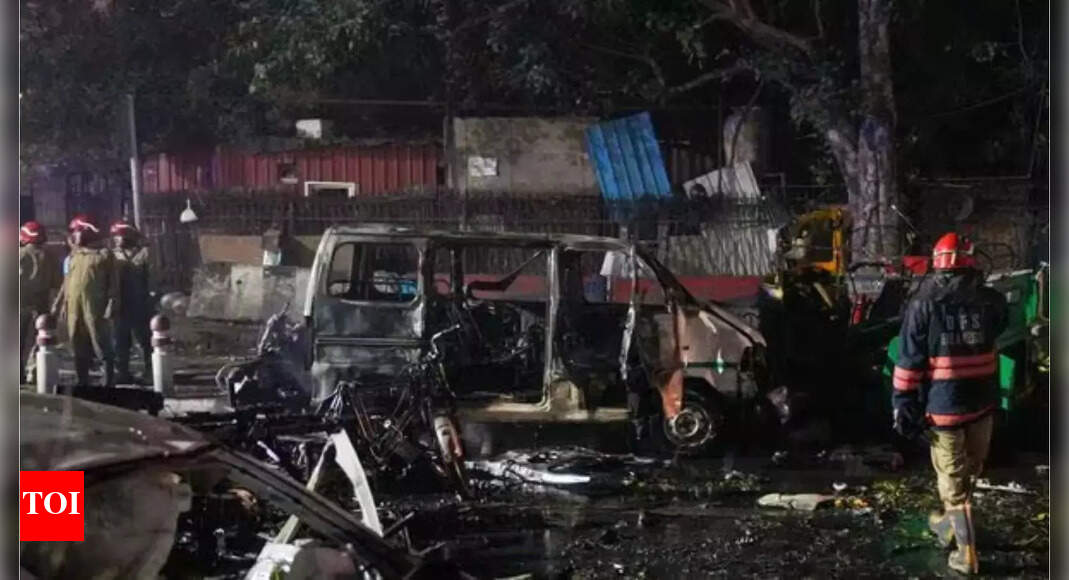A car explosion near Delhi’s Red Fort Metro Station on Monday evening claimed eight lives and injured twenty-four. The blast occurred in a Hyundai i20 at a traffic signal, damaging nearby vehicles. Authorities, including the NSG and NIA, are investigating. Prime Minister Modi and Home Minister Shah reviewed the situation and visited victims. Delhi blast (Agency photo) NEW DELHI: Delhi Police on Monday detained the owner of a car in which an explosion occurred near the Red Fort, an official told news agency PTI.Eight people were killed on Monday evening in a blast near Gate Number 1 of the Red Fort Metro Station. Delhi Police, along with teams from the Fire Department, the Forensic unit, the National Security Guard and the National Investigation Agency, are at the site to conduct inquiries. Prime Minister Narendra Modi and Union home minister Amit Shah reviewed the situation soon after the incident.Addressing the media, Shah said the explosion took place in a Hyundai i20 at the Subhash Marg traffic signal near the Red Fort, injuring some pedestrians and damaging multiple vehicles.Shah also visited the blast site with the Delhi top cop. Before his visit to the explosion site, the home minister visited the LNJP hospital to meet the blast victims.Twenty-four people were injured in the blast that took place on a busy evening when the area was milling with people. The injured were taken to the LNJP hospital, a few kilometres away.Hours after the incident, Shah, accompanied by senior police officers and doctors, met the injured at the hospital. He visited several wards of the hospital and interacted with the injured.Immediately after the blast, the home minister spoke to the Delhi police chief and the director of the Intelligence Bureau to take stock of the situation. He also directed the chiefs of the National Security Guard (NSG), National Investigation Agency (NIA) and forensic sciences to send expert teams to the blast site to assist the probe and collect evidence. Delhi Police Commissioner Satish Golcha has said that the situation is being monitored and information “is being shared with the home minister from time to time”.”Today at around 6.52 pm, a slow-moving vehicle stopped at the red light. An explosion happened in that vehicle, and due to the explosion, nearby vehicles were also damaged. All agencies, FSL, NIA, are here… Some people have died, and some have been injured in the incident. The situation is being monitored. The Home Minister has also called us, and information is being shared with him from time to time,” Golcha told news agency ANI.About the AuthorTOI News DeskThe TOI News Desk comprises a dedicated and tireless team of journalists who operate around the clock to deliver the most current and comprehensive news and updates to the readers of The Times of India worldwide. With an unwavering commitment to excellence in journalism, our team is at the forefront of gathering, verifying, and presenting breaking news, in-depth analysis, and insightful reports on a wide range of topics. The TOI News Desk is your trusted source for staying informed and connected to the ever-evolving global landscape, ensuring that our readers are equipped with the latest developments that matter most.”Read MoreEnd of ArticleFollow Us On Social MediaVideosTerror Angle in Delhi Blast Not Ruled Out: PM Modi Briefed, Home Minister Amit Shah Calls NIA, NSG‘Never Heard Such an Explosion’: Locals Recall Shock and Panic After Delhi BlastCar Blast Near Delhi’s Red Fort Leaves 8 Dead, Several Injured; City on High AlertPM Modi’s Bhutan Visit Turns Spiritual As Tobgay Calls Him Brother, Nation Awaits Global PrayerFaridabad Terror Plot: Woman Doctor Arrested After AK-47 Recovery, Experts Hint at Pakistan LinkMassive Car Explosion Near Delhi’s Red Fort Hours After Faridabad Terror Plot bust, Many DeadBJP Hits Out at Congress for Sidelining Tharoor After Advani Birthday WishPM Modi To Join Global Peace Prayer Festival As India-Bhutan Ties Reach New HeightsTop Bengaluru Jail Official Transferred, 2 Suspended After Viral Videos Spark Outrage23-Year-Old Indian Student Dies In Texas; Family In Andhra Pradesh Appeals For Help To Repatriate123PhotostoriesThese 5 animals are the largest to have roamed the Earth (One is still lives today)From heated arguments with VJ Paaru to special moments with FJ: Evicted contestant Praveen Raj’s Bigg Boss Tamil 9 journey4 foods to combine with Kiwi for a power-packed breakfast4 reasons to use Kusha Grass in daily puja ritualsDelhi Red Fort car blast: How a sudden explosion turned Delhi evening into chaos and fear5 trending Mangalsutra design ideas every modern bride should know about6 reasons why the humble bathua deserves a place of respect in global kitchens10 baby names that mean happiness in different languagesExclusive – From being a part of creative team to working with Shah Rukh Khan in Dil Toh Pagal Hai: Balvinder Singh Suri aka Roshan Sodhi of Taarak Mehta Ka Ooltah Chashmah on his journeyFrom Yam (Jimikand) to Colocasia (Arbi): 9 types of root vegetables found in India123Hot PicksBihar Election CandidatesBihar Election ConstituenciesBihar Election 2025Gold rate todaySilver rate todayPublic Holidays NovemberBank Holidays NovemberTop TrendingHafiz SaeedHailee SteinfeldVanessa BryantMarshawn Kneelands GirlfriendMichael Willis Cause of DeathCharlie KirksJuan SotoCandace OwensMLB Trade RumorsMatt Hardy