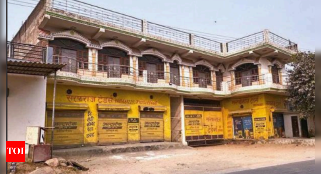 The building in Dhauj, Fbd, from where the explosives were found  GURGAON/SRINAGAR: A Kashmiri medical professor’s arrest has triggered one of the largest counterterrorism hauls in recent years, with investigators in J&K, Haryana and UP uncovering nearly 2,900kg of IED-making material, multiple assault rifles, pistols, chemicals, electronics and flammable substances. Police said a transnational module tied to Jaish-e-Mohammed (JeM) and Ansar Ghazwat-ul-Hind had allegedly embedded itself within academic and professional circles, using encrypted channels, charitable fronts and university networks to move funds, radicalise recruits and assemble explosives. The investigation began after threatening JeM posters appeared at several locations in Srinagar’s Bunpora Nowgam area on Oct 19.  An FIR under UAPA, Explosive Substances Act, and Arms Act was filed at Nowgam police station. Tracking the trail led police to what they described as a “white-collar terror ecosystem” of radicalised professionals and students allegedly in touch with handlers in Pakistan and other countries. Muzamil Shakeel, 35, a doctor from J&K’s Pulwama teaching at Al-Falah University in Faridabad’s Dhauj, was arrested October 30 after J&K police linked him to the posters. He managed the university hospital’s emergency wing and taught medical students. His questioning led Haryana and J&K police to two rented locations in Dhauj. Searches on Saturday at a room he allegedly took 15 days before his arrest yielded 358kg of suspected ammonium nitrate, a Krinkov assault rifle with three magazines, 83 live cartridges, a pistol, & bomb-making paraphernalia.Cops probing if Faridabad univ lab was used for making RDX Searches on Saturday at a room Muzamil Shakeel allegedly took 15 days before his arrest yielded arms, ammunition, explosive material and bomb-making paraphernalia: 12 suitcases and a bucket packed with explosives, 20 timers, batteries, remote controls, 5kg heavy metal, and a walkie-talkie set. Searches expanded Monday to Dehar Colony, also in Dhauj, where police found an additional 2,563kg of explosives and flammable material. Seized weapons include a Chinese pistol, a Beretta pistol, an AK-56 rifle, and a Krinkov rifle – all with ammunition. “The sheer volume of material points to plans for large-scale terrorist attacks,” a police officer said. Faridabad police spokesperson Yashpal said teams were working to identify accomplices, trace procurement chains, and determine the weapons’ source. “Raids are being carried out at multiple locations linked to the accused,” he said. Investigators have detained several people allegedly connected to Muzamil, including a religious scholar from a mosque near the university. Police said they are probing whether laboratory facilities at Al-Falah University were intended for synthesising advanced explosives such as RDX. An AK-47 allegedly linked to Muzamil was found in the Swift Dzire of a woman doctor from the same university. Officers said she has not been arrested and may have loaned her vehicle without knowing its use, but her role remains under scrutiny. She is currently being questioned in J&K. Before Muzamil’s arrest, UP’s Saharanpur police detained another Pulwama doctor – Adeel Majeed Rather. His interrogation led investigators to Dhauj and uncovered Muzamil’s alleged storage facility. Faridabad police commissioner Satender Kumar Gupta said a terrorist module was being designed. “Though I cannot reveal much as it concerns national security, joint teams of Haryana and J&K police have successfully busted a major terrorist network,” he said, adding that more arrests were expected. J&K police announced a broader breakthrough, calling it a “major counterterrorism operation” that dismantled an inter-state and transnational module linked to JeM and AGuH. Arrests include Arif Nisar Dar alias Sahil and Yasir-ul-Ashraf of Nowgam, Maqsood Ahmad Dar alias Shahid of Nowgam, Molvi Irfan Ahmad of Shopian, Zameer Ahmad Ahanger of Ganderbal, Dr Muzammil Ahmad Ganaie of Koil in Pulwama, and Dr Rather of Kulgam. Searches were carried out across Srinagar, Anantnag, Ganderbal, and Shopian, along with coordinated operations in Faridabad and Saharanpur. “Financial investigation regarding flow of funds is on and all linkages are being traced and addressed expeditiously,” police said, adding that the operation reflects determination to dismantle alleged terrorist networks operating across state lines and from foreign soil.About the AuthorNikhil SharmaNikhil Sharma, managing director & COO, South Asia at Radisson Hotel GroupEnd of ArticleFollow Us On Social MediaVideosPM Modi Expresses Grief Over Delhi Blast, Amit Shah Reviews Security MeasuresTerror Angle in Delhi Blast Not Ruled Out: PM Modi Briefed, Home Minister Amit Shah Calls NIA, NSG‘Never Heard Such an Explosion’: Locals Recall Shock and Panic After Delhi BlastCar Blast Near Delhi’s Red Fort Leaves 8 Dead, Several Injured; City on High AlertPM Modi’s Bhutan Visit Turns Spiritual As Tobgay Calls Him Brother, Nation Awaits Global PrayerFaridabad Terror Plot: Woman Doctor Arrested After AK-47 Recovery, Experts Hint at Pakistan LinkMassive Car Explosion Near Delhi’s Red Fort Hours After Faridabad Terror Plot bust, Many DeadBJP Hits Out at Congress for Sidelining Tharoor After Advani Birthday WishPM Modi To Join Global Peace Prayer Festival As India-Bhutan Ties Reach New HeightsTop Bengaluru Jail Official Transferred, 2 Suspended After Viral Videos Spark Outrage123PhotostoriesBollywood reunion tales of separation and rediscovery that touched every heartBollywood battle stories that ignite patriotism and celebrate valourNo gym needed: 7 effective home exercises to burn belly fatThese 5 animals are the largest to have roamed the Earth (One is still lives today)From heated arguments with VJ Paaru to special moments with FJ: Evicted contestant Praveen Raj’s Bigg Boss Tamil 9 journey4 foods to combine with Kiwi for a power-packed breakfast4 reasons to use Kusha Grass in daily puja ritualsDelhi Red Fort car blast: How a sudden explosion turned Delhi evening into chaos and fear5 trending Mangalsutra design ideas every modern bride should know about6 reasons why the humble bathua deserves a place of respect in global kitchens123Hot PicksBihar Election CandidatesBihar Election ConstituenciesBihar Election 2025Gold rate todaySilver rate todayPublic Holidays NovemberBank Holidays NovemberTop TrendingRed Fort blastDonald TrumpDelhi Car BlastSimone BilesMichael Willis Cause of DeathCharlie KirksJordon HudsonCandace OwensMatthew GoldenDennis Hildeby