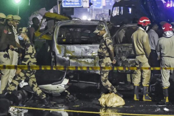 Diaries and notebooks seized from Al-Falah University rooms belonging to Dr Umar Mohammad and Dr Muzammil Ganaie have revealed a terror network of over 25 individuals. Coded entries, cryptic dates, and mentions of ‘operation’ suggest a larger, well-orchestrated plan for multi-city attacks, with fundraising of Rs 20 lakh for operational expenses.  NEW DELHI: In quiet corners of Al-Falah University, rooms 4 and 13 were hiding some chilling secrets — maybe a blueprint of terror disguised in diaries and notebooks. Investigators probing the Delhi Red Fort blast are now piecing together findings from diaries and notebooks, including codes, cryptic dates and notes left behind by suspects Dr Umar Mohammad and Dr Muzammil Ganaie.According to officials, diaries and notebooks were seized from Umar’s room number 4 and Muzammil’s room number 13, in the university’s building 17. They exposed a network of over 25 names, largely from Jammu and Kashmir and Faridabad. The diaries also mentioned dates from November 8 to 12 — the very window when the Red Fort blast took place on November 10, killing 13 people.ALSO READ: Delhi car blast probe: First image of Red Fort bomber Umar Un Nabi spotted near mosqueThe word ‘operation’ was repeatedly mentioned in the diaries, hinting at a larger and well-orchestrated plan. Room 13, occupied by Dr Muzammil, is the same place, just 300 meters away from where police had earlier unearthed 360 kg of explosives in Dhauj.Numbers, initials, and symbols: Secrets inside diaries  The recovered notebook contained coded entries — numbers, initials, and symbols — that intelligence teams are now decoding. Meanwhile, Room 4, where Dr Umar lived, revealed similar notes suggesting logistical coordination.ALSO READ: ‘Money dispute between docs’: 8 Delhi car blast suspects planned serial strikes across 4 cities — new details emerge(From top) Umar, Muzammil & ShaheenThe “white-collar terror” appears to have been two years in the making. According to sources, Umar and Muzammil, had quietly worked with other people under the cover of campus life. Investigators are now questioning a few university staff, including a hospital compounder for possible role in supplying materials or facilitating communication.Fundraising behind closed doors According to a news report from ANI, Dr Muzammil, Dr Adeel, Dr Umar, and Shaheen, accused in Delhi blast case, jointly raised approximately Rs 20 lakh in cash. The money was handed over to Umar for operational expenses. Sources revealed that the funds were allegedly used to procure over 20 quintals of NPK fertiliser worth around Rs 3 lakh from Gurugram, Nuh, and adjoining areas, for making IEDs.Doctors were planning multi-city deadly terror attackThe recovered notebooks and diaries are now at the heart of the investigation. The scribbled codes, dates and notes suggest that the i20 blast near the Red Fort may have been just one part of a broader operation. According to ANI, sources close to investigative agencies revealed that around eight suspects were allegedly preparing to execute coordinated explosions at four different locations across the country. Each pair was assigned to carry multiple improvised explosive devices (IEDs) for simultaneous attacks. A source told TOI, “The Delhi blast happened on Nov 10. Even if it was not meant to happen that day, the coded messages in the diaries suggest they were planning something big between Nov 8 and 12.”The sources told ANI that police successfully foiled major terror conspiracy involving a plan to carry out a series of blasts across multiple cities.What does the university say? Al Falah University in Haryana’s Faridabad, which is under the scanner, distanced itself from the terror-linked doctors. “We are deeply saddened and anguished by the unfortunate developments that took place and condemn the same. Our thoughts and prayers are with all the innocent people affected by these distressing events,” a statement issued by University vice chancellor prof (Dr) Bhupinder Kaur Anand said.”We have also learnt that two of our doctors have been detained by the investigating agencies. We wish to make it clear that the University has no connection with the said persons apart from them being working in their official capacities with the University,” she said.What happens nextThe probe has extended, focusing on supply chains — from those who provided batteries and rented vehicles to anyone who helped store explosives.About the AuthorTOI News DeskThe TOI News Desk comprises a dedicated and tireless team of journalists who operate around the clock to deliver the most current and comprehensive news and updates to the readers of The Times of India worldwide. With an unwavering commitment to excellence in journalism, our team is at the forefront of gathering, verifying, and presenting breaking news, in-depth analysis, and insightful reports on a wide range of topics. The TOI News Desk is your trusted source for staying informed and connected to the ever-evolving global landscape, ensuring that our readers are equipped with the latest developments that matter most.”Read MoreEnd of ArticleFollow Us On Social MediaVideosDhaka Burns Ahead Of Sheikh Hasina Verdict; Yunus Govt Struggles To Contain Unrest Across BangladeshDNA Confirms Red Fort Bomber Was J&K Doctor; Turkey Handler ‘Ukasa’ Orchestrated PlotMarco Rubio Praises India’s Handling Of Delhi Red Fort Blast Probe, Says India Doesn’t Need US HelpTerrifying CCTV Captures Delhi’s Red Fort Blast; Vehicles Erupt in Fireball’Terror May Strike Our Cities…’: Netanyahu Expresses Solidarity With India After Delhi Blast’Heinous Terror Attack’: Cabinet Passes Resolution On Delhi Blast, Swift Probe OrderedIndian Army Showcases Joint Combat Readiness In Jaisalmer During Exercise ‘Akhand Prahar’Red Fort Blast Had A Bigger Plan: Faridabad Doctor’s January 26 Recces Raise Chilling Questions’R&D Must Be Seen As Investment, Not Expenditure’: DRDO Chief Samir V KamatPenpa Tsering’s ‘No Hanuman’ Remark: Tibet’s Stark Message on Geography, Peace, and Survival123PhotostoriesBefore streaming took over, Bollywood’s global magic began with legends like Raj Kapoor, Shah Rukh Khan, Salman Khan and more5 Japanese techniques to have a happier, calmer, and stress-free lifeVijay Varma’s journey from selling SIM cards to silver screen: How the ‘Suriya 43’ star turned struggles into stardomInside Hyderabad’s HITEC City: The Powerhouse Driving Telangana’s Global Tech Transformation10 countries where education systems push students to their limits through rigorous examsHappy birthday, Juhi Chawla: Revisiting ‘Ishq’ actress’ best traditional looks over the yearsGrandma, who can sit down and mop floors at 100, shares 3 simple secrets of her long life and good healthMeet the richest billionaires in each continent across the worldBest Place To Manifest According To Your Birth DateFrom Preeti Jhangiani to Suchitra Krishnamoorthi: 90s Bollywood beauties who made us fall in love123Hot PicksBihar Election CandidatesBihar Election ConstituenciesBihar Election 2025Gold rate todaySilver rate todayPublic Holidays NovemberBank Holidays NovemberTop TrendingMarshawn KneelandMLB Trade RumorsMarvin Harrison JrAJ BrownMagic JohnsonBGMI 4.1 UpdateLaMelo BallKlay Thompson GirlfriendGiannis AntetokounmpoMichael Duarte Cause of Death