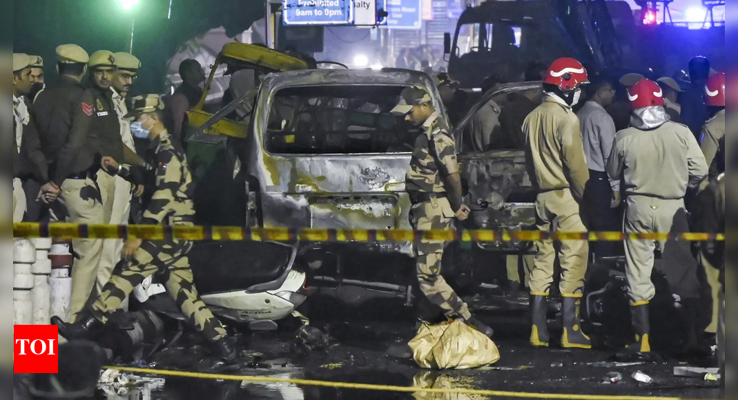 Diaries and notebooks seized from Al-Falah University rooms belonging to Dr Umar Mohammad and Dr Muzammil Ganaie have revealed a terror network of over 25 individuals. Coded entries, cryptic dates, and mentions of ‘operation’ suggest a larger, well-orchestrated plan for multi-city attacks, with fundraising of Rs 20 lakh for operational expenses.  NEW DELHI: In quiet corners of Al-Falah University, rooms 4 and 13 were hiding some chilling secrets — maybe a blueprint of terror disguised in diaries and notebooks. Investigators probing the Delhi Red Fort blast are now piecing together findings from diaries and notebooks, including codes, cryptic dates and notes left behind by suspects Dr Umar Mohammad and Dr Muzammil Ganaie.According to officials, diaries and notebooks were seized from Umar’s room number 4 and Muzammil’s room number 13, in the university’s building 17. They exposed a network of over 25 names, largely from Jammu and Kashmir and Faridabad. The diaries also mentioned dates from November 8 to 12 — the very window when the Red Fort blast took place on November 10, killing 13 people.ALSO READ: Delhi car blast probe: First image of Red Fort bomber Umar Un Nabi spotted near mosqueThe word ‘operation’ was repeatedly mentioned in the diaries, hinting at a larger and well-orchestrated plan. Room 13, occupied by Dr Muzammil, is the same place, just 300 meters away from where police had earlier unearthed 360 kg of explosives in Dhauj.Numbers, initials, and symbols: Secrets inside diaries  The recovered notebook contained coded entries — numbers, initials, and symbols — that intelligence teams are now decoding. Meanwhile, Room 4, where Dr Umar lived, revealed similar notes suggesting logistical coordination.ALSO READ: ‘Money dispute between docs’: 8 Delhi car blast suspects planned serial strikes across 4 cities — new details emerge(From top) Umar, Muzammil & ShaheenThe “white-collar terror” appears to have been two years in the making. According to sources, Umar and Muzammil, had quietly worked with other people under the cover of campus life. Investigators are now questioning a few university staff, including a hospital compounder for possible role in supplying materials or facilitating communication.Fundraising behind closed doors According to a news report from ANI, Dr Muzammil, Dr Adeel, Dr Umar, and Shaheen, accused in Delhi blast case, jointly raised approximately Rs 20 lakh in cash. The money was handed over to Umar for operational expenses. Sources revealed that the funds were allegedly used to procure over 20 quintals of NPK fertiliser worth around Rs 3 lakh from Gurugram, Nuh, and adjoining areas, for making IEDs.Doctors were planning multi-city deadly terror attackThe recovered notebooks and diaries are now at the heart of the investigation. The scribbled codes, dates and notes suggest that the i20 blast near the Red Fort may have been just one part of a broader operation. According to ANI, sources close to investigative agencies revealed that around eight suspects were allegedly preparing to execute coordinated explosions at four different locations across the country. Each pair was assigned to carry multiple improvised explosive devices (IEDs) for simultaneous attacks. A source told TOI, “The Delhi blast happened on Nov 10. Even if it was not meant to happen that day, the coded messages in the diaries suggest they were planning something big between Nov 8 and 12.”The sources told ANI that police successfully foiled major terror conspiracy involving a plan to carry out a series of blasts across multiple cities.What does the university say? Al Falah University in Haryana’s Faridabad, which is under the scanner, distanced itself from the terror-linked doctors. “We are deeply saddened and anguished by the unfortunate developments that took place and condemn the same. Our thoughts and prayers are with all the innocent people affected by these distressing events,” a statement issued by University vice chancellor prof (Dr) Bhupinder Kaur Anand said.”We have also learnt that two of our doctors have been detained by the investigating agencies. We wish to make it clear that the University has no connection with the said persons apart from them being working in their official capacities with the University,” she said.What happens nextThe probe has extended, focusing on supply chains — from those who provided batteries and rented vehicles to anyone who helped store explosives.About the AuthorTOI News DeskThe TOI News Desk comprises a dedicated and tireless team of journalists who operate around the clock to deliver the most current and comprehensive news and updates to the readers of The Times of India worldwide. With an unwavering commitment to excellence in journalism, our team is at the forefront of gathering, verifying, and presenting breaking news, in-depth analysis, and insightful reports on a wide range of topics. The TOI News Desk is your trusted source for staying informed and connected to the ever-evolving global landscape, ensuring that our readers are equipped with the latest developments that matter most.”Read MoreEnd of ArticleFollow Us On Social MediaVideosDhaka Burns Ahead Of Sheikh Hasina Verdict; Yunus Govt Struggles To Contain Unrest Across BangladeshDNA Confirms Red Fort Bomber Was J&K Doctor; Turkey Handler ‘Ukasa’ Orchestrated PlotMarco Rubio Praises India’s Handling Of Delhi Red Fort Blast Probe, Says India Doesn’t Need US HelpTerrifying CCTV Captures Delhi’s Red Fort Blast; Vehicles Erupt in Fireball’Terror May Strike Our Cities…’: Netanyahu Expresses Solidarity With India After Delhi Blast’Heinous Terror Attack’: Cabinet Passes Resolution On Delhi Blast, Swift Probe OrderedIndian Army Showcases Joint Combat Readiness In Jaisalmer During Exercise ‘Akhand Prahar’Red Fort Blast Had A Bigger Plan: Faridabad Doctor’s January 26 Recces Raise Chilling Questions’R&D Must Be Seen As Investment, Not Expenditure’: DRDO Chief Samir V KamatPenpa Tsering’s ‘No Hanuman’ Remark: Tibet’s Stark Message on Geography, Peace, and Survival123PhotostoriesBefore streaming took over, Bollywood’s global magic began with legends like Raj Kapoor, Shah Rukh Khan, Salman Khan and more5 Japanese techniques to have a happier, calmer, and stress-free lifeVijay Varma’s journey from selling SIM cards to silver screen: How the ‘Suriya 43’ star turned struggles into stardomInside Hyderabad’s HITEC City: The Powerhouse Driving Telangana’s Global Tech Transformation10 countries where education systems push students to their limits through rigorous examsHappy birthday, Juhi Chawla: Revisiting ‘Ishq’ actress’ best traditional looks over the yearsGrandma, who can sit down and mop floors at 100, shares 3 simple secrets of her long life and good healthMeet the richest billionaires in each continent across the worldBest Place To Manifest According To Your Birth DateFrom Preeti Jhangiani to Suchitra Krishnamoorthi: 90s Bollywood beauties who made us fall in love123Hot PicksBihar Election CandidatesBihar Election ConstituenciesBihar Election 2025Gold rate todaySilver rate todayPublic Holidays NovemberBank Holidays NovemberTop TrendingMarshawn KneelandMLB Trade RumorsMarvin Harrison JrAJ BrownMagic JohnsonBGMI 4.1 UpdateLaMelo BallKlay Thompson GirlfriendGiannis AntetokounmpoMichael Duarte Cause of Death