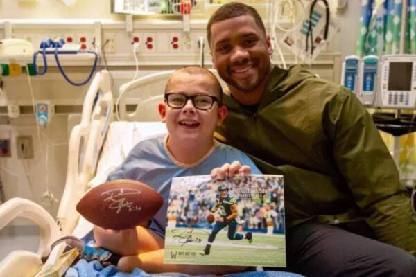Russell Wilson’s latest post captures a gentle moment with young patients, sparking heartfelt reactions online | NFL News