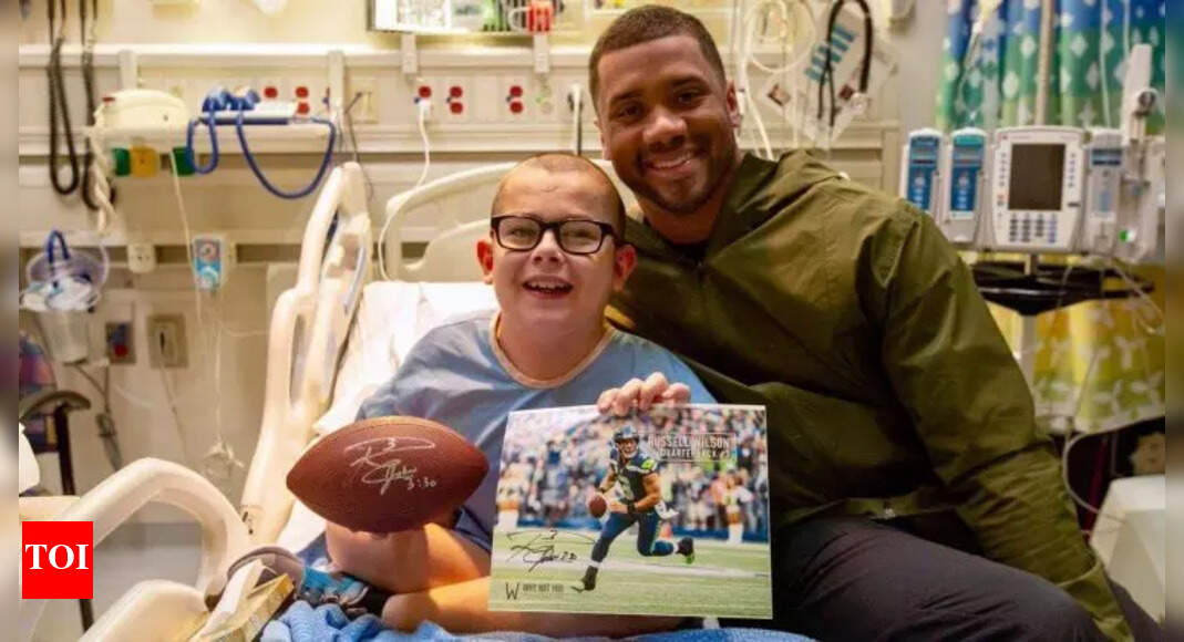 Russell Wilson’s latest post captures a gentle moment with young patients, sparking heartfelt reactions online | NFL News