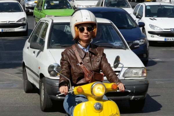 Iran: As traffic chokes Tehran, Women turn to motorbikes despite the ban