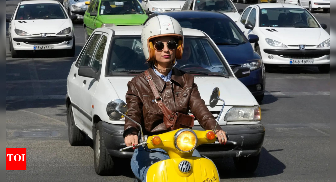 Iran: As traffic chokes Tehran, Women turn to motorbikes despite the ban