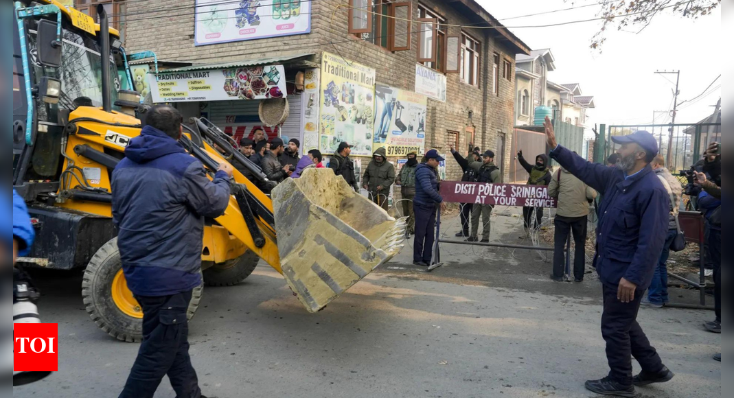 An accidental explosion at Nowgam Police Station in Srinagar killed nine people and injured 27 others. The blast occurred while processing a large cache of explosive substances and chemicals recovered during a terror module investigation. The ministry of home affairs has ruled out any terror angle, attributing the incident to the unstable nature of the seized materials. (PTI photo) NEW DELHI: The ministry of home affairs on Saturday ruled out any terror angle in the Nowgam police station blast case, terming it an “accidental explosion” that took place at the outskirts of Srinagar, killing 9 people and leaving several others injured.Deadly Explosion At Nowgam Station Exposes Scale Of 360 Kg Urban Terror Cache Seized From FaridabadAddressing a press briefing, Prashant Lokhande, joint secretary (J&K division), MHA, said: “Yesterday, at around 11:20 pm, an unfortunate accidental explosion took place inside the Nowgam Police Station.” “During the investigation of a terror module, a huge cache of explosive substances and chemicals had been recovered and kept securely in an open area of the police station.””As part of the standard procedure, these materials were being processed and forwarded for forensic examination.” “Due to their unstable and sensitive nature, they were being handled with utmost care. However, during the process, an accidental explosion occurred.””In this incident, nine people lost their lives, while 27 police personnel, two revenue officials, and three civilians sustained injuries. The injured were immediately rushed for medical care.””The police station building suffered severe damage, along with some surrounding structures. The cause of the accident is being investigated, and any other speculation is unnecessary.”Security personnel have cordoned off the area, and sniffer dogs have been deployed as part of the investigation.Jammu and Kashmir Police chief Nalin Prabhat also termed the massive explosion at the Nowgam police station as “accidental.”Prabhat said the explosives were recovered during the investigation of a “white-collar terror module” and had been transported from Faridabad in Haryana to the Nowgam police station, where they were kept in a secured open area within the premises.According to officials, the blast took place while a joint police and forensic team was examining the explosive material, which was part of a nearly 2,900 kg chemical cache recovered from an arrested doctor. The explosion triggered multiple secondary blasts and caused severe structural damage to the building.Sources said the probe is linked to the November 10 Delhi blast and to alleged objectionable posters found in Nowgam in October, which led to an FIR on October 19 and subsequent action against what was believed to be an inter-state Jaish-e-Mohammed module.Between October 20 and 27, two suspects were arrested from Shopian and Ganderbal, followed by the arrest of Dr Adil from Saharanpur on November 5. This led to the seizure of weapons and ammunition, including an AK-56 rifle, from Anantnag hospital and further arms and explosives from Faridabad.During interrogation, the accused allegedly named more persons involved, resulting in the arrest of Dr Muzammil of Al-Falah Medical College in Faridabad and additional recoveries of weapons and explosives.About the AuthorTOI News DeskThe TOI News Desk comprises a dedicated and tireless team of journalists who operate around the clock to deliver the most current and comprehensive news and updates to the readers of The Times of India worldwide. With an unwavering commitment to excellence in journalism, our team is at the forefront of gathering, verifying, and presenting breaking news, in-depth analysis, and insightful reports on a wide range of topics. The TOI News Desk is your trusted source for staying informed and connected to the ever-evolving global landscape, ensuring that our readers are equipped with the latest developments that matter most.”Read MoreEnd of ArticleFollow Us On Social MediaVideos‘Bengal Is Far-Fetched…’ Bengal Minister Shashi Panja Hits Back at PM Modi’s Jungle Raj Jibe‘Very Bleak Message To World’: South Africa Envoy Condemns Delhi Blast And Seeks Joint Action“All options open…” Piyush Goyal on ongoing India-Canada talks after two rounds of discussionsUN Must Reform Now: India Demands Expansion of Both Permanent And Non-Permanent UNSC Member StatesDeadly Explosion At Nowgam Station Exposes Scale Of 360 Kg Urban Terror Cache Seized From Faridabad‘Bihar’s New MY Formula Is Mahila & Youth’: PM Modi Targets RJD-Congress After NDA’s Landslide Win‘Too Big To Fail’: South African Envoy On Trump’s G20 Boycott, Says PM Modi’s Presence Crucial‘Misa-Priyanka Ko Dickey Mein…’: Yashwant Deshmukh’s Message to RJD–Cong After NDA’s Bihar WinAir India Bombing Returns To Spotlight, CSIS Warns Canada Of New Extremist Networks And Rising RisksSix Ways Nitish Kumar Proved ‘Tiger Abhi Zinda Hai’ As NDA Registers Big Win in Bihar Assembly Polls123PhotostoriesRaising Kids Who Love Learning (Not Just Getting Good Grades)Cute baby nicknames inspired by colorsFrom film stars to business leaders five Bollywood women shaping empires outside cinema7 lesser-known health benefits of drinking 1 glass of okra water with a tablespoon of lemon juice for a monthBudget-friendly ways to create a child’s own space even in a small homePancreatic cancer: How lifestyle choices can lower your riskZero sugar, big damage? The bone health impact of diet soda5 easy exercises for building strong legs5 trending white gown designs for a traditional Christian weddingRed flags men ignore: 7 physical signs that may indicate fertility issues123Hot PicksAlinagar Election ResultRaghopur Election ResultBihar Election Result 2025Gold rate todaySilver rate todayPublic Holidays NovemberBank Holidays NovemberTop TrendingLaMelo BallGiannis AntetokounmpoJoel EmbiidAidan HutchinsonNHL Trade RumorLatin GrammyDak PrescottBrazilian Bodybuilder Found DeadPercy HarvinStephen Curry