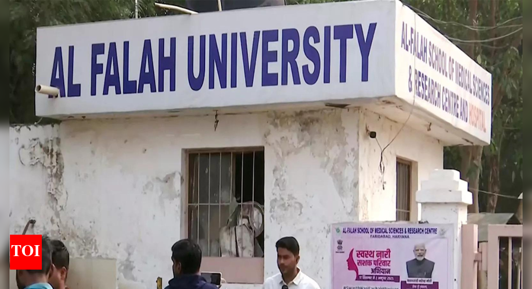 Delhi Crime Branch has registered two FIRs against Al-Falah University for cheating and forgery, following serious irregularities flagged by UGC and NAAC. The university is also under scrutiny after three doctors from its medical faculty were arrested in connection with a terror module linked to banned outfits. Al-Falah University (ANI image)  NEW DELHI: The Delhi Crime Branch on Saturday registered two FIRs against Al-Falah University over serious allegations of cheating and forgery. A team from the Delhi Crime Branch visited the university’s office in Okhla today. Delhi Police has also issued a notice to the institution, demanding a set of documents as part of their inquiry.The legal action follows serious irregularities flagged by the University Grants Commission (UGC) and the National Assessment and Accreditation Council (NAAC) during their assessments.According to police, the first FIR involves violations under Section 12 (cheating). The second FIR concerns alleged false accreditation claims made by the university.NAAC on Thursday has also served a show-cause notice to the Al-Falah School of Engineering and Technology, accusing it of claiming accreditation despite failing to complete the mandatory renewal process. The council stated that the university was last accredited in 2013 with a ‘B’ grade but did not submit required documents like the Self-Study Report even after repeated reminders. NAAC has warned that its earlier accreditation may be declared “null and void”.The university is already under intense scrutiny after the Delhi Red Fort blast on November 10, in which 13 people were killed and several others were injured.Investigators have arrested three doctors from Al-Falah’s medical faculty. These include: Dr Muzammil Ganaie, Dr Umar Un Nabi and Dr Shaheen Shahid for their alleged involvement in a terror module linked to banned outfits Jaish-e-Mohammed and Ansar Ghazwat-ul-Hind. Police say the group was trying to target students and medical professionals for radicalisation. Dr Shaheen was allegedly planning to flee to Dubai but was arrested recently after the recovery of weapons and explosives from vehicles traced to the university campus. Over the past week, more individuals linked to them, including two MBBS students have been detained from Nuh.Established in 1997 and run by a charitable trust based in Okhla, Al-Falah University expanded from an engineering college to a 70-acre campus that now includes a medical college and an 800-bed hospital.About the AuthorTOI News DeskThe TOI News Desk comprises a dedicated and tireless team of journalists who operate around the clock to deliver the most current and comprehensive news and updates to the readers of The Times of India worldwide. With an unwavering commitment to excellence in journalism, our team is at the forefront of gathering, verifying, and presenting breaking news, in-depth analysis, and insightful reports on a wide range of topics. The TOI News Desk is your trusted source for staying informed and connected to the ever-evolving global landscape, ensuring that our readers are equipped with the latest developments that matter most.”Read MoreEnd of ArticleFollow Us On Social MediaVideosEAM Jaishankar, Russian FM Lavrov To Hold Talks In Moscow On Nov 17 Ahead Of Putin’s India TripAir Marshal AK Bharti Reveals Why India Ended Operation Sindoor After Achieving Its Core ObjectiveWTO DG Okonjo-Iweala Lauds India’s Trade Strategy, Calls For Multilateral LeadershipPakistan Rejects Taliban Narrative And Says Rising Terror From Afghan Soil Can No Longer Be IgnoredNDA Sweeps Bihar, Nitish Kumar Prepares for 10th CM Oath; A Look Back at ‘Sushasan Babu’s’ JourneyPiyush Goyal Says India Ready For WTO Leadership, Rejects Reform Agendas Pushed By Developed NationsJ&K Police Confirm 9 Killed in Nowgam Blast After Explosives Recovered From Faridabad Blows UpPM Modi Predicts Major Congress Split After NDA’s Bihar Win And Warns Allies Of Growing Instability‘Bengal Is Far-Fetched…’ Bengal Minister Shashi Panja Hits Back at PM Modi’s Jungle Raj Jibe‘Very Bleak Message To World’: South Africa Envoy Condemns Delhi Blast And Seeks Joint Action123PhotostoriesExclusive – Bigg Boss 19: Mridul Tiwari reacts to his eviction, calls Farrhana Bhatt ‘toxic’ and ‘evil’, and comments on Amaal Mallik’s image being ‘white-washed’Animal protein vs plant protein: Which is best for meeting the body’s nutritional needs?10 phrases parents should never tell a childHow to grow juicy beetroot in pots for a blooming balcony gardenAkshaye Khanna, Annu Kapoor to Swara Bhasker: How online frauds tricked these Bollywood celebrities out of lakhsHow to rewear your wedding lehenga this wedding seasonThe ideal bedtime routine order for school-age kidsMassive infrastructure push: Ahmedabad to get three lifeline flyovers by 2026Mumbai’s Big Shift: Inside BMC’s Plan for a 1,000-Dog Mulund Shelter7 animals with the most attractive and expressive eyes!123Hot PicksAlinagar Election ResultRaghopur Election ResultBihar Election Result 2025Gold rate todaySilver rate todayPublic Holidays NovemberBank Holidays NovemberTop TrendingLaMelo BallGiannis AntetokounmpoJoel EmbiidAidan HutchinsonNHL Trade RumorLatin GrammyDak PrescottBrazilian Bodybuilder Found DeadPercy HarvinStephen Curry