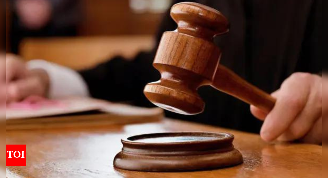 NEW DELHI: It was not the sort of work that is associated with state machinery. The court of additional sessions judge Shefali Barnala Tandon (of the Patiala House courts) was convened at her residence around 3 am on Friday to remand a person accused of money laundering, Swaraj Singh Yadav, in ED’s custody. Yadav, who is the promoter of Ocean Seven Buildtech Pvt Ltd, is accused of illegally selling PM Awas Yojana flats in Gurgaon in all-cash transactions.After a daylong search, Yadav was held by the agency before midnight on Thursday. ED’s move came in connection with the alleged laundering of more than Rs 222 crore of funds generated from illegal sale of apartments meant for the poor under PM Awas Yojana. These were sold at an inflated price of Rs 40-50 lakh each to new buyers by cheating the original allottees whose allotment was cancelled, with not even their deposits being refunded. The original cost of a flat was Rs 26.5 lakh.Realtor running ‘nationwide laundering scam’, says ED Using these funds, ED said, the accused acquired personal assets, including 500 acres at Ware village in Maharashtra, 100 acres on Pune-Alibag Road, Sai Rupa Resorts in Tirthan Valley in Himachal Pradesh and land in Boston (US), besides financial assets in the UK.”The search for the arrestee started at 6.55 am, and he has to be produced before the court within 24 hours of the search, as per the guidelines of Supreme Court and various high courts,” the ED submitted before the judge while producing the accused “at this odd hour” at her residence. The legal counsel of the accused was still on his way when the court began its proceedings at 3.05 am, and by the time the hearings from both the sides concluded, it was 6.30 am. The judge remanded the accused in ED’s custody till Nov 28, when he is to be produced again. Not taking a chance, the judge specifically instructed that the accused be brought before the court at 2 pm on that day.The ED accused Yadav of committing “a nationwide money laundering scam since 2006, duping thousands of buyers in Mumbai, Jaipur, Kotputli and Gurugram”. As per FIRs registered against him with the Delhi police, an estimated Rs 222 crore of homebuyers’ money was siphoned by the accused after layering them through a related “in-house construction agency”.”The concerted and accelerated liquidation of both personal and company-held assets by arrestee Swaraj Singh Yadav in the recent past strongly indicates his intent to dispose of the proceeds of crime and escape action under provisions of law. The investigation records confirm the urgent disposal of assets and liquidation of funds in anticipation of legal action. He had already sold a flat in Jalvayu Vihar in Gurugram, 40 acres of land in Borgaon, Maharashtra, and 15 acres in Jaipur,” the ED said.”This coincides with his wife Sunita Swaraj relocating to the US in Aug 2025,” the agency added and brought to the notice of the court the fact that the accused had transferred huge amounts to the US via a bank account of his wife’s in Bank of Baroda. With his children pursuing graduation from Trinity College, Connecticut, US, there is every possibility of his fleeing from justice, the agency said.End of ArticleFollow Us On Social MediaVideos’MMC’: PM Modi Mocks Congress After NDA’s Bihar Win; Calls It ‘Muslim League Maoist’ Party‘Abandoned Tribals To Their Fate’: PM Modi Accuses Congress Of Neglecting Tribal CommunitiesCDS General Anil Chauhan Highlights Inter-Service Jointness And Integration In Op SindoorEAM Jaishankar, Russian FM Lavrov To Hold Talks In Moscow On Nov 17 Ahead Of Putin’s India TripAir Marshal AK Bharti Reveals Why India Ended Operation Sindoor After Achieving Its Core ObjectiveWTO DG Okonjo-Iweala Lauds India’s Trade Strategy, Calls For Multilateral LeadershipPakistan Rejects Taliban Narrative And Says Rising Terror From Afghan Soil Can No Longer Be IgnoredNDA Sweeps Bihar, Nitish Kumar Prepares for 10th CM Oath; A Look Back at ‘Sushasan Babu’s’ JourneyPiyush Goyal Says India Ready For WTO Leadership, Rejects Reform Agendas Pushed By Developed NationsJ&K Police Confirm 9 Killed in Nowgam Blast After Explosives Recovered From Faridabad Blows Up123Photostories6 ancient 10-minute yoga poses that will help sharpen memory and increase focus5 must-have pieces for a winter capsule wardrobeMahesh Babu to Priyanka Chopra: 5 best celebrity looks of the day5 easy exercises for shoulder painreliefSmelling this fragrance can instantly improve focus and supercharge the brain, and no, it’s not coffee6 easy and science-backed snacks that fight colon cancerMold Toxicity: How to recognize its symptoms that appear like a common cold7 phrases parents can say instead of ‘No’ to kidsExclusive – Bigg Boss 19: Mridul Tiwari reacts to his eviction, calls Farrhana Bhatt ‘toxic’ and ‘evil’, and comments on Amaal Mallik’s image being ‘white-washed’Animal protein vs plant protein: Which is best for meeting the body’s nutritional needs?123Hot PicksAlinagar Election ResultRaghopur Election ResultBihar Election Result 2025Gold rate todaySilver rate todayPublic Holidays NovemberBank Holidays NovemberTop TrendingCarey Price WifeArjun TendulkarTyreek HillsDubai Prince Sheikh Hamdan Net WorthZack RyderPat NarduzziJack DohertyWayne Gretzkys SonDak PrescottPercy Harvin