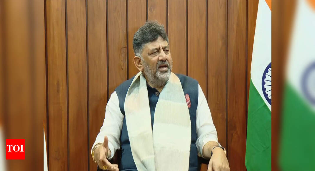 DK Shivakumar NEW DELHI: Karnataka deputy chief minister DK Shivakumar on Sunday asserted there is “no need” for him to step down as the state Congress president, stressing that his health is “good” and that he has several responsibilities to discharge as Karnataka Pradesh Congress Committee (KPCC) chief. “I have worked to build the party day in and day out, and I will continue to do so. My mental, physical and political health is good,” he told reporters in Bengaluru, according to ANI.Shivakumar noted that he must oversee the laying of foundation stones for 100 Congress party offices in Karnataka and is scheduled to meet Congress president Mallikarjun Kharge. “We have to celebrate the Congress foundation day (December 28). Who will do all this? I have to do it. Why should I resign from the KPCC presidency? There is no need for it,” he remarked. Describing himself as a “loyal soldier” of the party, he added that he would continue as KPCC chief for as long as the leadership wants him to remain in the role.On whether he would raise rumours of a Cabinet reshuffle during his meeting with Kharge, Shivakumar distanced himself from the matter. “That is left to the CM (Siddaramaiah). He will discuss it with the high command. I am meeting Kharge only to finalise dates for laying the foundation for the new Congress offices. I would like both Mallikarjun Kharge and Rahul Gandhi to lay the foundation stone. I am requesting a date before December 1 as the Parliament session starts that day,” he explained. Shivakumar’s reaffirmation of loyalty comes amid a renewed push from a section of the Karnataka Congress for him to be elevated as chief minister under the so-called “2.5-year formula” that party leaders had reportedly agreed upon after returning to power in May 2023, defeating the BJP.About the AuthorTOI News DeskThe TOI News Desk comprises a dedicated and tireless team of journalists who operate around the clock to deliver the most current and comprehensive news and updates to the readers of The Times of India worldwide. With an unwavering commitment to excellence in journalism, our team is at the forefront of gathering, verifying, and presenting breaking news, in-depth analysis, and insightful reports on a wide range of topics. The TOI News Desk is your trusted source for staying informed and connected to the ever-evolving global landscape, ensuring that our readers are equipped with the latest developments that matter most.”Read MoreEnd of ArticleFollow Us On Social MediaVideosNIA Arrests Alleged Aide Of ‘Suicide Bomber’ Umar Nabi In Delhi Terror AttackEAM Jaishankar Meets Qatar’s Top Leadership In Doha, Reaffirms Commitment To Stronger TiesSGPC Mulls Banning Lone Women In Pilgrim Jathas After ‘Missing’ Punjab Woman Marries Pakistani ManRSS-Linked Youth Shot Dead In Punjab’s Firozpur, Probe UnderwayKerala: RSS Worker Dies By Suicide After BJP Denies Local Body Poll Ticket In Thiruvananthapuram1 Dead, Several Feared Trapped As Portion Of Stone Mine Collapses In UP’s Sonbhadra; Rescue Ops On”I have no family…” Rohini Acharya Cuts Ties With Lalu Clan, Exits Politics Post-RJD DefeatRK Singh Slams Bihar BJP Suspension, Says He Only Opposed Tickets to Criminal Candidates‘Premature to Speculate’: Tharoor Hits Back at Farooq Abdullah Over Operation Sindoor Remarks‘Nitish Still X-Factor’ Pavan Verma Decodes Why Jan Suraaj Couldn’t Break Through in Bihar Polls123Photostories5 home exercises for Parkinson’s diseaseJournaling for beginners: 5 simple ways to start your de-stress journey5 ways to deepen connection without sending long emotional texts7 Cs of a champion mindset to drive success7-day infused water challenge that will reduce blood sugar levelsHow Bollywood actress Deepika Padukone inspires modern moms with grace and strength5 unsung women freedom fighters of the Indian race to Independence5 most expensive foods in the worldUnseen childhood pictures of Shraddha Kapoor with Shakti Kapoor, Siddhant, and Lata Mangeshkar you can’t miss5 timeless Swami Vivekananda quotes to inspire students on their journey123Hot PicksAlinagar Election ResultRaghopur Election ResultBihar Election Result 2025Gold rate todaySilver rate todayPublic Holidays NovemberBank Holidays NovemberTop TrendingKayla NicoleArjun TendulkarJames Harden girlfriendDubai Prince Sheikh Hamdan Net WorthRCB IPL RetentionBengaluru Techie Shoes MissingUS VisaIslam makhachev net worthDelhi BlastCharlie Mcavoy Injury