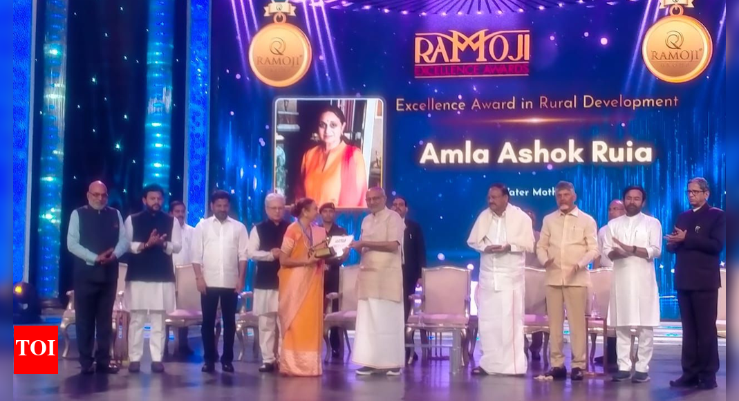 Amla Ashok Ruia  honoured with ‘Excellence in Rural Development’ award  NEW DELHI: Amla Ashok Ruia, popularly known as the “Water Mother,” was honoured with “Excellence in Rural Development” award at the inaugural Ramoji Excellence Awards 2025 held at Ramoji Film City in Hyderabad.Her recognition stood out as a tribute to her transformative work in rural empowerment and sustainable community development, making her one of the evening’s most celebrated awardees.Vice-President C P Radhakrishnan presented the award to Amla Ashok Ruia in the presence of Telangana chief minister A Revanth Reddy, Andhra Pradesh chief minister N Chandrababu Naidu and governor of Telangana Jishnu Dev Varma, among others.Ruia, through her Aakar Charitable Trust, has restored livelihoods, water security and hope across rural India. She has transformed drought-prone villages through innovative water-harvesting initiatives.The Ramoji Excellence Awards, instituted in memory of Sri Ramoji Rao garu, has been launched to honour individuals who embody the values of service, discipline, and nation-building and whose contributions strengthen the nation’s moral and intellectual foundations. The inaugural ceremony acknowledged seven distinguished personalities across diverse fields.In his keynote address, Vice-President Radhakrishnan said, “Sri Ramoji Rao garu was a visionary who transformed ideas into institutions and dreams into enduring realities. He was not only a pioneer in media and communication but a true nation-builder. His commitment to truth, ethics, and excellence continues to inspire generations across the entire nation.”Alongside Ruia, eminent personalities such as Jaideep Hardikar (Excellence in Journalism), Shri Srikanth Bolla (Youth Icon Award), Pallabi Ghosh (Women Achiever Award), and Prof Madhavi Latha Gali (Excellence in Science & Technology) were also honoured.End of ArticleFollow Us On Social MediaVideosPak Army Chief Asim Munir Vows ‘Strong Response’, Army Chief Dwivedi Warns Op Sindoor Was A TrailerPM Modi Condoles Families as 45 Indians Feared Dead in Saudi Bus CrashOusted Bangladesh PM Hasina Calls ICT’s Death Sentence ‘Rigged’, Says It Denied Fair Trial RightsFrench Consulate Staffer Molested In Bandra As Mumbai Police Launch Rapid Hunt To Track The SuspectAfter 5th August 2019…’ Army Chief Counters Mehbooba’s Charge Against Centre Over J&K SituationChennai Gripped By Panic As Bomb Threats Target MK Stalin, Ajith Kumar, Top Tamil Nadu Personalities’Snow Must Melt’: Army Chief Dwivedi Details How India China Relations Shifted After 2024 TalksIndia Sends Strong Warning To Pakistan As Army Chief Says The Real Movie Begins After Op SindoorBangladesh On Edge: Ex-PM Sheikh Hasina Rejects Evidence, Son Issues Threat Before Tribunal VerdictOver 40 Indians From Hyderabad Travelling From Mecca To Medina Feared Killed in Saudi Bus Crash123PhotostoriesBharti Singh gets emotional as she gets a surprise baby shower from Laughter Chefs team; friends Krushna Abhishek, Tejasswi Prakash, Jannat Zubair and others attend the bash8 easy exercises to increase your child’s height10 cities in the US where rent is below ,0005 quiet habits of partners who deeply trust each other9 street foods to enjoy in Amritsar during winterHow to grow karela (bitter gourd) from seeds at home in your balcony7 foods that kids love but they slowly damage their teethHow rejected roles in ‘Munna Bhai MBBS’, ‘DDLJ’ and ‘Barfi’ made Sanjay Dutt, Shah Rukh Khan and Deepika Padukone unforgettable2025 Tata Sierra: Design, features, specs explained in imagesInside Bhopal’s 600-acre Ijtema: 7 lakh devotees, 300 nikahs, 240 food stalls123Hot PicksDelhi AQI TodaySheikh Hasina VerdictBihar Government FormationGold rate todaySilver rate todayPublic Holidays NovemberBank Holidays NovemberTop TrendingKayla NicoleAaron Rodgers InjuryShedeur SandersDubai Prince Sheikh Hamdan Net WorthRohini AcharyaDraymond GreenLebron JamesPaige GrecoZelina VegaCharlie Mcavoy Injury