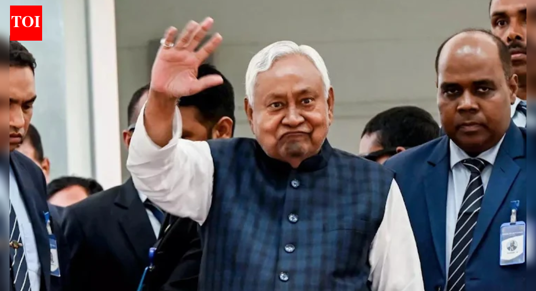 Nitish Kumar secures an unprecedented tenth term as Bihar’s Chief Minister, demonstrating remarkable political resilience. Despite numerous alliance shifts and criticisms, he has once again swept the state, shattering notions of age-related fatigue. His consistent victory, attributed to strategic governance and welfare initiatives, solidifies his position as a dominant force in Bihar’s politics. Nitish Kumar sworn-in as Bihar chief minister for 10th time NEW DELHI: Phir ek baar Nitish Kumar. Bihar, once again, has sealed its political future in the hands of a man who has ruled it for most of the past two decades — a leader who has mastered the art of survival, reinvention, and political engineering like no one else in modern politics. With a thunderous NDA majority of 202 seats, the state has handed Nitish Kumar his 10th chief ministerial term, an extraordinary milestone he reached on November 20, 2025.The relentless, “nirantar” Nitish Kumar has once again eased into the chief minister’s chair in Bihar — a testament to his reputation as an “all-weather politician.” At 74, he continues to wield influence with remarkable ease, comfortably reaffirming his place at the centre of the state’s politics.Nitish Kumar To Take CM Oath For Record 10th Time At Patna’s Gandhi Maidan, PM Modi To AttendFor a politician who has been written off more times than he can count, Nitish Kumar stands today not merely as a survivor but as a phenomenon — a leader who breaks political arithmetic, escapes anti-incumbency, defies public resentment, and returns to the top regardless of the alliances he breaks or builds.Whether Nitish Kumar’s image as ‘Sushasan Babu’—the leader long associated with development, stability, and restored law and order—still genuinely resonates, or whether years of political fatigue, policy stagnation, and serial flip-flops have dulled that sheen, is a debate that never quite settles in Bihar. But what is undeniable is this: despite every doubt, every switch, every storm, Nitish has once again swept the state broadly into his corner.This time, the win is emphatic.This time, the message is unmistakable.This time, even the “Joe Biden of Bihar” label — about age, fatigue, and diminishing appeal — has been shattered.Nitish Kumar, with this “lion majority,” has emerged as the most popular face in the state, silencing critics and reaffirming that “Nitish sabke hain.”From Bakhtiarpur to the top: The man who doesn’t lose the chairBorn on March 1, 1951, in Bakhtiarpur, Nitish Kumar began not with political ambition but with electrical engineering. But it was social engineering that became his lifelong calling.His political roots were shaped in the JP movement, where he was among the thousands jailed during the Emergency in Indira Gandhi’s era. He won his first assembly election in 1985 from Harnaut, briefly supported Lalu Prasad Yadav in 1989, and then broke away — beginning a rivalry that would define Bihar politics for decades.In 1994, Nitish quietly engineered the first major rebellion against Lalu. Fourteen MPs broke away under George Fernandes — but insiders knew Nitish was “the brain.” The group soon became the Samata Party, marking his decisive ideological shift.Two years later, he made his first big flip — aligning with the BJP in 1996. This alliance would form, break, reform, and rupture again and again over the next three decades.He entered the Vajpayee cabinet, holding the railway ministry and other portfolios from 1998–2004. His administrative style, focus on law and order, and reform-mindedness gradually shaped his technocratic image.His first shot at the CM’s chair came in 2000, but the NDA lacked numbers. His government fell in just seven days.But Nitish was not done. He was only beginning.The era that changed BiharIn 2005, Nitish Kumar returned — this time ending Lalu Prasad Yadav’s 15-year rule, often dubbed as “jungle raj” by many and inaugurating what many call Bihar’s “reconstruction era.”His 2010 victory solidified his hold over the state, establishing him as the face of development-based politics. Women-centred welfare — bicycles, uniforms, prohibition, jobs, and cash transfers — created what scholars call a maternal welfare state. Nitish did this better than almost anyone.One man, many switchesAnd yet, his political journey is not defined only by governance — but by U-turns.At least six times since 1999, Nitish has switched between the NDA and the UPA or Mahagathbandhan camps.This earned him the label “Paltu Kumar”.In 2013, he snapped ties with the BJP after Narendra Modi became its PM face — a move that cost him dearly.In 2015, he joined the RJD-Congress Mahagathbandhan and returned as CM with Tejashwi Yadav as deputy.In 2017, he walked out overnight, resigned, and came back as NDA CM the same evening — his most dramatic switch ever.In 2022, accusing the BJP of trying to break the JD(U), he left again and rejoined the Mahagathbandhan.In 2024, he switched back to the BJP-led NDA and reclaimed the chief minister’s post — a dramatic reversal considering he had just helped stitch together what was touted as India’s one of the grandest-ever opposition alliance, the INDIA bloc, formed explicitly to counter the BJP. Yet, in classic Nitish fashion, he eventually folded the experiment and returned to his old ally.And now in 2025, the alliance has delivered its most decisive mandate in decades: 202 seats, with BJP’s 89, JD(U)’s 85, and strong support from Chirag Paswan’s LJP (RV), HAM, and RLM.In each case, Nitish emerged on the winning side — not weakened, but strengthened.As Machiavelli wrote: “Whosoever desires constant success must change his conduct with the times.”Few Indian politicians embody that insight better.Defeating the hegemon, again and againNitish didn’t just defeat Lalu Prasad Yadav in 2005 — he defeated the entire idea of invincible caste-based politics in Bihar.In 2025, he did it again.The Nitish-led NDA stormed past 200 seats, crushing the Tejashwi-led Mahagathbandhan, reducing the RJD to just 25 seats — limiting it to just one-third of what it got in 2020. Nitish’s own JD(U) rose to 85 seats, its highest in a decade.The man from Bakhtiarpur faced zero anti-incumbency. If anything, his long stay in power became an asset.The Nitish model of staying in powerThe secret behind Nitish Kumar’s political immortality lies in four fundamentals:1. He never contests Assembly electionsNitish last contested and won an assembly election in 1985.He contested once more in 1995, won, and then switched to Parliament permanently.Since then, he has always taken the legislative council (MLC) route.His famous line: “I chose to become an MLC by choice… the Upper House is a respectable institution.”Keeps his popular face beyond caste and communal lines.2. He becomes indispensable to every allianceIn 2020, the BJP was bigger (74 seats) – yet gave Nitish the CM chair.In 2022, the RJD was larger (75 seats) – yet made Nitish the CM again.His image is universal: “Nitish sabke hain.”3. Welfare + governance = political immunityThe bicycle scheme, women’s welfare transfers, reservation expansions, prohibition, cash incentives — Nitish shifted Bihar’s politics from caste solidarity to material empowerment.4. He is the ultimate crisis navigatorParty splits, ideological shifts, electoral losses — he absorbs the shocks better than any contemporary leader.A record-breaking 10th termIn 2025, Nitish Kumar stands on the cusp of an unmatched milestone — his 10th oath as chief minister. Outside the Northeast, no leader in India has come close to such continuity.He is also in line to break the record of Sikkim’s Pawan Chamling and Odisha’s Naveen Patnaik to break the record of longest serving chief minister ever in India.The turbulence, the U-turns, the comebacks — none of it derailed him.Instead, each twist only confirmed what Bihar has now declared with a historic mandate:No matter the alliance. No matter the arithmetic. No matter the storm. Nitish Kumar remains chief minister.End of ArticleFollow Us On Social MediaVideosUS Approves Major Arms Deal For India With Javelins And Excalibur To Counter Regional Threats”We Are Done…” Trump Recalls Critical Modi Call That Averted India-Pakistan Nuclear ClashNitish Kumar To Take CM Oath For Record 10th Time At Patna’s Gandhi Maidan, PM Modi To AttendBangladesh To Seek Interpol’s Help To Extradite Sheikh Hasina From India’Fatwa Issued…’: BJP Jabs ‘Indira Nazi Congress’ For Criticising Tharoor Over Modi Speech PraiseRussia Showcases Missile-Only Pantsir SMD-E Air Defence System At Dubai Airshow 2025’We Hit India…’: Pakistani Leader’s Explosive Admission Unmasks Islamabad’s Terror Links Again’Can’t Rule Out All-Out War’: Pakistan’s Khawaja Asif Rattled Over Army Chief’s Sindoor 2.0 WarningSydney Horror Crash Kills 8-Month Pregnant Indian After Teen BMW Driver Slams Into Family WalkIndia Expands Its Diplomatic Presence In Russia As Jaishankar Highlights Strategic New Consulates123PhotostoriesRevisiting Ranveer Singh’s most iconic street style and standout fashion moments5 things every parent should tell their child when they face body shaming6 Buddhist techniques to stop overthinking10 life lessons from Lord Hanuman every kid should knowVitamin B12: Signs your body is running low (and why most people don’t notice them)Morning mantras for children for a sharp mind and gentle heart10 life changes that happen when you begin a spiritual journey (that no one talks about)Aishwarya Rai Bachchan’s top 5 important parenting lessons for today’s generationKriti Sanon can’t stop wearing sarees, and each look is more iconic than the last5 lesser-known dangerous animals around the world123Hot PicksDelhi AQI TodaySheikh Hasina VerdictBihar Government FormationGold rate todaySilver rate todayPublic Holidays NovemberBank Holidays NovemberTop TrendingTrevon DiggsTom BradyMLB SignsDraymond GreenCanara Bank Manager RobberyFortnite DownTop Stock RecommendationsGold Silver Price PredictionStefon DiggsBaker Mayfield Wife