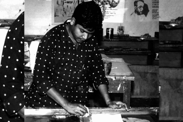 In the early 1980s, Jangarh Singh Shyam’s art on a mud wall in Patangarh village was recognized as contemporary art by J. Swaminathan. This led to the global emergence of “Gond painting,” though many insist on calling it “Jangarh Kalam” to honor its individual creator and revolutionary style.  On a humid monsoon afternoon in the early 1980s, in a village most Indians had never heard of, a Delhi artist stood silently before a mud wall. The village was Patangarh, deep inside the Mandla forests of Madhya Pradesh. The wall belonged to a modest Gond home. And on that wall, painted in earth pigments and improvised brushes, a teenage boy had created a world that seemed to move – snakes curling into rivers, birds morphing into trees, forest spirits floating above hills, every surface breathing with lines, dots and patterns.The visitor, painter and thinker J Swaminathan, instantly sensed that this was not “tribal craft” or “folk ornamentation.” It had structure, language, confidence. It was, unmistakably, contemporary art. The boy was named Jangarh Singh Shyam. Within a decade, his work would travel from Patangarh to Bhopal, from Bhopal to Delhi, and eventually to Tokyo and Paris – carrying with it an idiom that came to be known worldwide as “Gond painting.” Those closest to him, however, insist that the truer name is “Jangarh Kalam.”The forest, the hill and the painted wallLong before the words “Gond painting” appeared in gallery catalogues or GI-tag notifications, there were just mud walls, red earth and the slow, attentive labour of village hands. In the forested belt of central India, in and around Patangarh in Madhya Pradesh’s Mandla district, painting was not a profession but a way of keeping faith with the world.The Gond and Pardhan communities who live here have long believed that every hill, river, tree and rock is inhabited by spirit. Art grew out of that belief. Images of tigers, peacocks, serpents, women, ancestors and deities were painted on the inner and outer walls of homes using what the land provided: charcoal for black, geru and other clays for warm reds and browns, chhui mitti for pale yellow or white, crushed leaves for green, plant sap and cow dung as binders.These images were not “artworks” in the contemporary sense. They were part of rituals marking harvests, marriages, festivals and propitiations to Bada Dev, the Gonds’ great god. The practice — digna and bhitti chitra — sat alongside oral traditions: the songs of Pardhan bards, the sound of the single-stringed bana, the stories of origins, animals and gods. The aesthetic was functional, sacred and collective.What did not exist yet was a single, named, portable “Gond painting” style. Different villages had different motifs, and the marks on the wall faded with time, rain and replastering. The leap from wall to canvas, from ritual to recognised art form, would come much later — and decisively through one young artist from Patangarh.From ritual markings to narrative artWhen we speak of Gond painting today, we are usually referring to a visual language built up from fine lines, dots and dashes, filling animal and human forms with pulsating pattern and colour. Horses, stags, fish, birds and trees are often shown in improbable combinations: a tree that is also a bird, a river that coils like a snake, a tiger whose body is made of leaves.These choices are not random decoration. They grow out of the community’s close observation of the forest, but they are also filtered through individual imagination and memory. As Mayank Singh Shyam, elder son of the late painter Jangarh Singh Shyam, explains of his father’s work:“This art emerged from my father’s soul and imagination, and on that foundation, it received the identity of a distinct style. The term ‘Gond painting’ is neither historically accurate nor rooted in our traditional practices. In India, artistic styles like Mithila, Madhubani, Warli, and Kalighat carry clear geographical identities. But Patangarh never received such recognition, and my father never called himself the creator of any ‘Gond’ style.”His description underlines two important things. First, that what we now call Gond painting is rooted in older wall traditions, but is not simply a direct transfer of those motifs. And second, that the form in which the world sees it today was decisively shaped by one individual.“I call it the Jangarh Style, because this was a revolutionary and completely new artistic form born from my father, the late Jangarh Singh Shyam. For the first time, someone created a stylistic form based on tribal memory, experience and tradition. Before him, the mural markings and motifs in our region did not have an independent artistic identity.“If you read research papers from the 1970s, you will not find any reference to ‘Gond painting’. This name was assigned later, merely because an Adivasi artist had created paintings drawn from his imagination and life experience.”The boy whose imagination lifted that visual memory onto paper and canvas grew up in the very landscape he painted — in Patangarh, among hill slopes whose very name, many scholars point out, echoes the Dravidian root kond or konda for green hill.The moment Patangarh entered the art mapThe turning point came in the early 1980s, when the currents of urban modern art met the currents of tribal expression in Bhopal. The mediator between these worlds was J Swaminathan — painter, poet, Marxist intellectual and one of the key figures behind Bharat Bhavan, the multi-arts complex that opened in 1982.At Bharat Bhavan, Swaminathan set up the Roopankar Museum of Folk and Tribal Art with a clear conviction: that tribal and folk artists were not anonymous “craftspeople” but contemporaries of any modern painter, thinking in their own visual philosophies. To make that visible, he travelled widely through the tribal belts of Madhya Pradesh, looking for artists whose work broke the frame of mere ritual.In 1981, that search brought him to Patangarh. On the mud walls of a house, he saw something that startled him: brilliantly imaginative scenes painted with a sureness of line that felt entirely personal rather than formulaic. The hand behind them was a teenager, Jangarh Singh Shyam.Swaminathan brought him to Bhopal. For the young painter, the move meant not just a change of geography but of medium and gaze. At Bharat Bhavan, he was given paper, canvas, brushes and poster colours. The walls of his childhood were replaced by surfaces that would not be plastered over. His images could now travel; they could be exhibited, sold, collected.In this new environment, the motifs of Patangarh began to expand. Birds and animals were no longer just auspicious elements in a domestic ritual; they became central protagonists in dense narrative fields. Trees grew bodies, gods inhabited forests, and the patterns of dots and lines began to act almost like musical notation — echoing the community’s bardic tradition in visual form.Jangarh kalam: When a style finds its nameAs these works began to circulate, critics and curators saw that something new was happening. This was not simply a documentation of tribal life for urban consumption; it was an authorial vision.Working at Bharat Bhavan, and later in other cities and abroad, Jangarh developed a distinctive technique: inner and outer contour lines drawn with great precision, and figures filled with comb-like strokes, rows of ovals, scales and squiggles that created an intense sense of movement. The surfaces of his paintings glowed with deep reds, electric blues and greens, bright yellows and speckled textures.The art world began to refer to this as “Jangarh Kalam” — the pen or style of Jangarh. Over time, however, as more artists from Patangarh and elsewhere adopted and adapted this vocabulary, the broader label “Gond painting” took hold, especially in the market and among urban buyers.For his family and many of his peers, this shift in terminology remains unresolved. The label “Gond painting” links the work to community identity, but it also risks erasing the very individuality that allowed it to enter the world in this form. Mayank voices that tension sharply:“People still look at traditional wall drawings and say they want the ‘traditional type of work’. They send me my father’s paintings as reference. They don’t know this is not tradition—it is a new style.“It is like salt—you cannot see it, but you taste it. You can see my father’s influence in every artist’s work. That essence is not Gond—it is Jangarh.”For the purposes of history, both terms now sit side by side: Gond painting as the larger field, Jangarh Kalam as a crucial, defining stream within it.Untitled Carousel     A village of paintersAs Jangarh’s reputation grew, so did the number of brushes and Rotring pens in Patangarh. Young men and women from the village and the surrounding Mandla forests began training, first informally, then as apprentices. Some learnt directly from him in Bhopal or during his visits; others studied his works that travelled back home.Names like Anarkali Shyam, Champi Bai Shyam, Rajesh Shyam, Santosh Maravi, Sanjay Pancheshwar and many others emerged from this context. Their paintings transformed “traditional musical memory into imaginative contemporary visuals”, as one exhibition curator put it: fairytale-like images crafted out of fine lines, scales and dots that vividly express stories based on folklore and mythology. In these canvases, animals grow into trees, trees merge into forests that seem to reach the gods, and the human figure often appears small in a world dominated by nature.The shift from charcoal and mud pigment to acrylics and ink did not mean an abandonment of older themes. Instead, it allowed them to be archived, traded and displayed. Red began to stand for the heat of the sun, yellow for energy, green for the forest’s life, blue for calmness and tranquillity. The language of colour, once dictated by whatever the soil and leaves could provide, now also responded to market demands and exhibition lighting.At the same time, Gond painting retained a quality that set it apart from much urban art: a persistent refusal to place humans at the centre of the universe. Trees, tigers, elephants and peacocks are often the real protagonists. The paintings become both celebration and warning — quietly rebelling against deforestation, urban decay and the loss of habitat by insisting, again and again, on the primacy of the more-than-human world.New stories, new mediumsWhile many Patangarh artists continued to work in a vocabulary close to Jangarh’s, others took seriously his advice that each artist must find their own way. Nowhere is this more visible than in the work of his daughter, Japani Shyam.She grew up literally at his side: “My father is my guru. I learnt painting from him. I was very young at that time, but I still worked with him. From time to time, he would teach me things while working on his paintings, and I would follow what he showed me.“The style comes naturally. Whoever learnt from him, you can see his influence in all their work. I have seen my father doing highly experimental work. He always said that every artist should create their own distinct style.”Watching him create dazzling, highly coloured works filled with detail, she chose to move in a visually opposite direction, without abandoning the underlying grammar.“My father always worked in very colourful compositions with a lot of detailing. Detailing has always been part of our work, but I felt that I should bring something different into my own work.“In traditional Gond painting, there are bright, vibrant colours and a lot of detailing. People recognise a Gond painting immediately. In the beginning, I also worked exactly like my father.“But remembering what he told all of us — ‘create your own style’ — I started working in just two colours, with a white background. At first, people could not understand it, because they were used to seeing Gond paintings in very bright colours. So black-and-white looked very different to them.“Gradually, I explained that the story is still the same, the same nature, the same themes — I only changed the colours and medium. That is how my work began to acquire a separate identity.”Her canvases often centre women and contemporary life as much as forests and animals:“In our traditional Gond painting, the focus is mainly on nature — trees, birds, animals. That still exists, but now I take ideas from what I see in front of me.“Whether it is the city, the village, or the lives of women — most of my work has been centred around women. I observe the surroundings where I live: city life, village life, what is happening in the present time, and I work on that.“Instead of creating long mythic stories, I now work on real things around me. That is what makes my work a little different from others.”In doing so, she embodies one of the most striking features of Gond painting today: its ability to remain rooted in ritual and nature while absorbing the pressures and textures of the present — from migration and urbanisation to gendered experience.Lineage, labour and the question of authenticityThe growing popularity of Gond painting, especially in urban fairs and online platforms, has raised a familiar problem in folk and tribal arts: how to tell the difference between deep, rooted work and shallow imitation. Japani’s response to this is less about policing than about attention:“As you start understanding something deeply, you begin to recognise quality in one glance.“Today many people like Gond painting, but only a few truly understand it. On the internet, in fairs, there are many artists — some from our community, some not — all working under the name ‘Gond painting’.“Some people just think it is Gond painting, no matter who made it. But there are others who know the artist’s name, understand the story and what is actually being conveyed.“I think only those who have a genuine interest in art, and who know and understand it, can truly identify which work is deeper and distinct.”Her favourite works of her father say something about what that depth looks like: “It’s very difficult for me to choose five, because I love all of my father’s work. But personally, I especially love his works based on gods and goddesses.“The way he painted gods and goddesses — whether in drawings or colourful paintings — was entirely his own style. Their eyes, faces, mouths, noses, the jewellery, the adornment — everything was very detailed and imaginative.“Perhaps nobody imagined our deities like that before. But he created them through his imagination in such a way that they do not look frightening or wrong — just astonishing.”In those faces — neither sanitised nor terrifying — one can glimpse what made his work, and by extension Gond painting as we know it, so singular.A journey that ended in JapanIf the story of Gond painting’s rise has the feel of a fairytale — a boy from a remote village discovered by a renowned modernist, his work travelling to museums in Tokyo, Paris and London — its central figure’s death remains a stark reminder of the vulnerabilities behind such trajectories.In 2001, while working in Japan, Jangarh died in circumstances that have since been described in official records as suicide. For his family, the questions around that moment remain raw. Mayank says simply:“This question has lived in my mind for 25 years. What happened with my father remains unanswered. Why did it happen in Japan, even though he had already travelled there twice earlier? Who facilitated his travel? Under what circumstances did everything unfold there? The truth is still unknown.“People say he was depressed, but we never knew of him taking any such medication. He loved us deeply. We could not even see him one final time—his body came home after ten days. We could not embrace him and cry.“It is the deepest wish of my mother, my siblings and mine that we go to Japan and light a lamp at the place where he breathed his last.”For the art, however, that journey from Patangarh to Japan left a lasting mark. Large murals in Japanese museums, international exhibitions in Europe and America, and high-profile sales turned Gond painting from an almost entirely local practice into a recognised category in the global art market.Recognition, gaps and the role of the stateDespite this international acclaim, the recognition accorded at home has been uneven. Jangarh received the Madhya Pradesh government’s Shikhar Samman, and his works have entered major Indian collections. Yet, as Mayank points out, the scale of his contribution — creating an entire stylistic movement and opening a path for dozens of artists — has not been fully matched by institutional honour:“Despite creating such a revolutionary artistic movement, 25 years have passed and the government has given nothing beyond the Shikhar Award. The students he trained received honours. But the one who created the style did not. That is the biggest mistake.“We all artists believe that if this style is officially recognised as the ‘Jangarh Style’ or ‘Jan-Kalam’, it would be the greatest tribute to him.”Their demand is not only personal. It speaks to a broader question: can the state and the art establishment recognise individual Adivasi artists not merely as representatives of a community form, but as authors of styles and movements? The GI tag for Gond painting from Madhya Pradesh acknowledges geographic and community origin; what Mayank and others seek is a similar clarity around authorship within that field.Why Gond painting still needs a new audience at homeGlobally, Gond painting — especially works from the Jangarh lineage — enjoys a steady presence. Exhibitions in Paris, London, Tokyo and New York, illustrated books, collaborations with designers and international collectors have all kept demand alive. Mayank notes from experience:“In India, people still don’t fully understand how important this art is. I have just returned from exhibiting in Paris. Abroad, there is deep respect for it. But in India, awareness is still lacking. That is why media has a crucial role.”That role involves more than celebrating “tribal art” in occasional features or festivals. It means telling the story of how a village like Patangarh became a hub of contemporary practice; how women like Japani have taken the line and dot further into new subjects; how younger artists are using the Gond vocabulary to speak of climate anxiety, migration, caste and gender. And it means listening carefully when those within the tradition say that names matter — that “Gond painting” is not a flat, singular thing, but a field in which Jangarh Kalam occupies a defining place.From mud walls washed away each monsoon to canvases that hang in climate-controlled galleries thousands of kilometres away, the journey of Gond painting is not just a story of art. It is a story of how imagination travels: from a boy in a forest village painting what he sees and dreams, to a family and a community who continue to hold that line steady, even as the world looks on.About the AuthorAyush PandeyAyush Pandey is a journalist at the Times of India. He covers breaking news, political developments, and key legal and policy shifts across India and the world, with a focus on politics, elections, and institutional affairs.

He also specialises in analytical explainers and in-depth feature stories that examine the broader implications of political alliances, policy changes, and evolving public sentiment.Read MoreEnd of ArticleFollow Us On Social MediaVideosManipur Sangai Festival 2025- ThemeSangai Festival 2025 Opening CeremonyEx-VP Jagdeep Dhankhar Breaks Silence, Calls Out Narrative Traps With Cryptic Reference To His Past’This Is How Democracy Should Work’: Shashi Tharoor’s Truth Bomb on Cong After Trump-Mamdani MeetingChina Used India-Pak Hostilities For Real-World Weapon Tests And Global Arms Sales, Says US ReportRSS Chief Mohan Bhagwat Warns Civilisations Will Fade But Hindus Endure While Calling For UnityIndia Urges Stronger Global Action At UN As Navy’s 520 Rescues Spotlight Arabian Sea InstabilityAt Indo-Pacific Forum, Pakistan Claims India Endangering Peace With War Rhetoric, IWT SuspensionBravery In The Sky: The Story Of Namansh Syal, Tejas Pilot Who Died During The Dubai Airshow DisplayAustralian PM Condoles Red Fort Attack, Saudi Bus Tragedy As He Meets PM Modi During G20 Summit123PhotostoriesStep-by-step guide for growing Kiwi in your balcony gardenTomato Price Hike: 11 delicious & healthy tomato substitutes to try’Barfi’, ‘Black’ to ‘Masaan’: Bollywood films where actions speak more than words5 Signs your child may be struggling with depression and how you can helpMumbai’s Rs 100-Crore Footpath Revamp: What’s Changing on Key RoadsThe must-have vaccines every child needs: What parents shouldn’t skip9 gorgeous white animals that reflect nature’s elegance9 regional chicken dishes from across IndiaActor who lost 10 films overnight after a set accident with Amitabh Bachchan, went jobless for 6 years, is now…How Bengaluru’s Vande Bharat Sleeper Rake Aims to Transform Long-Distance Travel123Hot PicksDelhi AQI TodayBihar Minister List 2025Bihar CM Oath CeremonyGold rate todaySilver rate todayPublic Holidays NovemberBank Holidays NovemberTop TrendingPortland Trail Blazers vs Golden State WarriorsSavannah JamesMiami Heat vs Chicago BullsSophie CunninghamHow to get Vecna Skin in FortniteAdam FootePM ModiLebron JamesNBA CupCade Cunningham