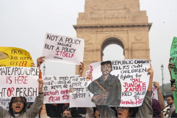Anti-pollution protests in Delhi turned political as demonstrators displayed pro-Maoist posters, leading to over 22 arrests. Police reported protesters used chilli spray on personnel. The BJP labelled them ‘professional protesters’ and ‘urban Naxals.’ Meanwhile, Aam Aadmi Party questioned the BJP-led Delhi government’s “inaction” on the pollution as the air quality remained “very poor” in the region.  NEW DELHI: Chilli sprays, pro-Maoist posters and over 22 arrests characterised the anti-pollution protests in the national capital region on Sunday. The protests turned political, with the Bharatiya Janata Party leaders bringing the “urban Naxals” narrative to the demonstrations.Meanwhile, Aam Aadmi Party questioned the BJP-led Delhi government’s “inaction” on the pollution as the air quality remained “very poor” in the region.’We Can’t Breathe’: Activists, Parents, Kids Held During Delhi Clean-Air Protest At India GatePeople had also gathered at the same location on November 9, urging the government to enforce measures to reduce air pollution in the NCR.Hidma posters on displayVisuals from the protests showed the demonstrators holding posters of Maoist commander Madvi Hidma, who was recently killed in an encounter.”A protest was held this evening at C Hexagon, India Gate, over pollution. But the protesters were holding posters of Maoist commander Madvi Hidma. When they tried to block the road, the police tried to remove them, but they sprayed pepper spray on the police personnel and tried to attack them. The police are now taking legal action against them,” ANI quoted Delhi Police saying.Hidma, a CPI(M) central committee member and the secretary of the Dandakaranya Special Zonal Committee, was killed on November 18 along with his wife, Rajje, and four other Maoists in the Maredumilli forests of Andhra Pradesh’s Alluri Sitarama Raju district. Security forces had said the group initiated firing during a cordon-and-search operation, sparking an extended encounter.Reacting to this, Chhattisgarh deputy chief minister Vijay Sharma said that the “children had no idea what they were actually talking about.””The children had no idea what they were actually talking about. They mentioned ‘Jantana Sarkar’, but they have neither seen it themselves nor understood its real impact. They are kids; they will understand eventually. Still, they need to learn how democracy functions, how real governments are formed, what their purpose and existence are, and how they actually operate,” he said.Delhi Police narrates what went on groundAccording to the Delhi Police, over 15 protesters were arrested after they allegedly refused to disperse during a demonstration against rising pollution at the C-Hexagon near India Gate. Police said the protesters obstructed official work, blocked the road, and, even more unusually, used chilli spray on police personnel.”Some of the protesters gathered inside the C-Hexagon and then tried to cross the barricade that we had put in place to restrict movement. However, they did not comply; they broke the barricade, came onto the road, and sat there…We requested them to move, as many ambulances and medical personnel were waiting behind them and required emergency access…We removed them from the C-Hexagon to avoid disrupting traffic. During the removal, several protesters scuffled with the police, and many of our personnel were injured,” ANI quoted Devesh Kumar Mahla saying.An FIR was registered, and relevant sections were invoked for assaulting police officers, causing obstruction, and blocking public pathways.BJP calls them ‘professional protesters’BJP leader Shahnawaz Hussain slammed the demonstrators, calling them “professional protesters” for “raising slogans in support of Hidma”.”They came claiming to protest against pollution, but that was not their real purpose. Those with a ‘polluted mind’ began raising slogans in support of Hidma. We have always said that urban Naxals are present in cities as well,” he said.”In the forests, we have eliminated them, and whatever remains will also be finished. ‘Professional protesters’ always look for excuses against the government. Pollution was just a pretext – they aimed to promote Naxalism,” he added.”Under the pretext of pollution, some Naxalite elements staged a protest at India Gate and openly violated every norm of democracy. While protesting, they raised pro-Naxal slogans and sprayed chilli spray directly into the eyes of the police personnel on duty. This clearly shows it was a pre-planned conspiracy in which they failed. Such acts can never be accepted in a democracy,” said BJP MP Praveen Khandelwal.AAP leader Priyanka Kakkar, however, questioned the Delhi government, demanding “emergency meeting” to address the issue of pollution.”This is a national health emergency… The central government should act like a responsible government. It’s been 10 months since they’ve been in Delhi. Have you heard a single step they’ve taken regarding pollution? Nothing at all,” she said.”They should call a meeting with all the Chief Ministers and the Environment Ministers of the NCR, hold an emergency meeting, lay out certain plans, and take certain steps… This government is committing fraud with people’s health. That is why you are seeing citizens protesting again and again in Delhi: they, too, have understood the fraud of this government,” she added.About the AuthorTOI News DeskThe TOI News Desk comprises a dedicated and tireless team of journalists who operate around the clock to deliver the most current and comprehensive news and updates to the readers of The Times of India worldwide. With an unwavering commitment to excellence in journalism, our team is at the forefront of gathering, verifying, and presenting breaking news, in-depth analysis, and insightful reports on a wide range of topics. The TOI News Desk is your trusted source for staying informed and connected to the ever-evolving global landscape, ensuring that our readers are equipped with the latest developments that matter most.”Read MoreEnd of ArticleFollow Us On Social MediaVideosSuicide Bombers Storm Pakistan’s FC Headquarters In Peshawar As Explosions Rock High-Security ZoneJustice Surya Kant, Known For Article 370 Ruling And Pegasus Scrutiny, Takes Oath As India’s New CJI’We May Have Run Away!’: Cyril Ramaphosa’s Joke To PM Modi on Hosting G20 Summit Sparks LaughterHow AQ Khan Became ‘Merchant Of Death’ And Triggered Musharraf’s Outrage, Reveals Ex CIA OperativeIndia, Canada Restart Trade Talks, Aim For -Bn Trade By 2030 As Pm Modi Meets Mark CarneyIndia, Italy Launch Joint Initiative To Counter Terror Financing As PM Modi Meets MeloniPiyush Goyal Meets PM Netanyahu, President Herzog As India-Israel FTA Talks Gain Momentum‘Sindh May Return To India Again’: Rajnath Singh’s Big Remark On India-Pakistan Border’No Longer Optional’: PM Modi Calls For UNSC Reforms At IBSA Meet; Urges United Stand Against Terror‘Extensive Misinformation’: French Navy Slams Pakistan Media Report Over Op Sindoor Claims123PhotostoriesKyunki Saas Bhi Kabhi Bahu Thi fame Sandeep Baswana and Ashlesha Sawant marry after 23 years of living together; share dreamy wedding photosOnce Akshay Kumar, late Irrfan Khan, Manoj Bajpayee’s co-star, THIS actor lost everything and was forced to work as a watchmanKalyani Priyadarshan: Best fashionable moments7 interesting ways to ensure your kids eat eggsAishwarya Rai Bachchan’s approach to raising a confident daughterRoyal babies of 2025: A look at the famous Royal kidsTeaching kids: Who is a stranger? Understanding safe vs. unsafe peopleTop 7 baby names inspired by Lord ShivaHow to make Indian-style kimchi at home for a probiotic boost5 common mistakes people make on the first date123Hot PicksDelhi AQI TodayNew Labour CodeChennai rainGold rate todaySilver rate todayPublic Holidays NovemberBank Holidays NovemberTop TrendingChip KellyAuston Matthews InjuryCola Social Security PaymentsBrittany MahomesCanada Citizenship ActMichael IrvinSmriti MandhanaJosh Allen InjuryTejas CrashFortnite Chapter 7 Leaked
