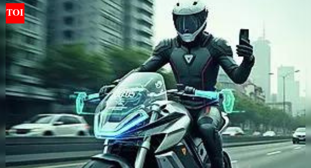 Image used for representative purposes NEW DELHI: Government is looking at a technology-based solution to curb the growing menace of two-wheeler riders using mobile phone handsets while driving or performing stunts, which contribute to road crashes. The plan involves installing touch or pressure sensors on both handlebars of two-wheelers so that if the rider’s hands are off the handle/s for more than 7-8 seconds, the vehicle would automatically begin to de-accelerate, forcing the person to ride properly.TOI has learned that the plan to use technology to correct rider behaviour was discussed at length at a meeting of transport ministry officials with vehicle manufacturers recently. Officials believe that such a mechanism could significantly reduce distracted riding, particularly the practice of holding a mobile phone in one hand while navigating traffic with the other, as well as performance of stunts.Many riders continue to flout basic safety norms despite penalties under the Motor Vehicles Act. “If the vehicle itself can sense unsafe behaviour and respond, it will deter risky behaviour without requiring constant policing,” said an official.Alongside handlebar sensors, manufacturers have been urged to explore the feasibility of providing leg guards on two-wheelers. This feature can reduce the severity of lower-limb injuries, which are among the most common in motorcycle crashes. While leg guards were more common in older models, modern two-wheelers do not have them.Government data shows there has been a steep rise in the number of two-wheeler deaths – from 69,385 in 2021 to 77,539 in 2023, nearly 45% of all road deaths. Two-wheeler riders top both as victims and cause of road fatalities. According to the road transport ministry’s report, two-wheeler riders had the highest share of road deaths in 2023 while 48,181 people were killed in accidents caused by them.End of ArticleFollow Us On Social MediaVideosSuicide Bombers Storm Pakistan’s FC Headquarters In Peshawar As Explosions Rock High-Security ZoneJustice Surya Kant, Known For Article 370 Ruling And Pegasus Scrutiny, Takes Oath As India’s New CJI’We May Have Run Away!’: Cyril Ramaphosa’s Joke To PM Modi on Hosting G20 Summit Sparks LaughterHow AQ Khan Became ‘Merchant Of Death’ And Triggered Musharraf’s Outrage, Reveals Ex CIA OperativeIndia, Canada Restart Trade Talks, Aim For -Bn Trade By 2030 As Pm Modi Meets Mark CarneyIndia, Italy Launch Joint Initiative To Counter Terror Financing As PM Modi Meets MeloniPiyush Goyal Meets PM Netanyahu, President Herzog As India-Israel FTA Talks Gain Momentum‘Sindh May Return To India Again’: Rajnath Singh’s Big Remark On India-Pakistan Border’No Longer Optional’: PM Modi Calls For UNSC Reforms At IBSA Meet; Urges United Stand Against Terror‘Extensive Misinformation’: French Navy Slams Pakistan Media Report Over Op Sindoor Claims123PhotostoriesKyunki Saas Bhi Kabhi Bahu Thi fame Sandeep Baswana and Ashlesha Sawant marry after 23 years of living together; share dreamy wedding photosOnce Akshay Kumar, late Irrfan Khan, Manoj Bajpayee’s co-star, THIS actor lost everything and was forced to work as a watchmanKalyani Priyadarshan: Best fashionable moments7 interesting ways to ensure your kids eat eggsAishwarya Rai Bachchan’s approach to raising a confident daughterRoyal babies of 2025: A look at the famous Royal kidsTeaching kids: Who is a stranger? Understanding safe vs. unsafe peopleTop 7 baby names inspired by Lord ShivaHow to make Indian-style kimchi at home for a probiotic boost5 common mistakes people make on the first date123Hot PicksDelhi AQI TodayNew Labour CodeChennai rainGold rate todaySilver rate todayPublic Holidays NovemberBank Holidays NovemberTop TrendingChip KellyAuston Matthews InjuryCola Social Security PaymentsBrittany MahomesCanada Citizenship ActMichael IrvinSmriti MandhanaJosh Allen InjuryTejas CrashFortnite Chapter 7 Leaked