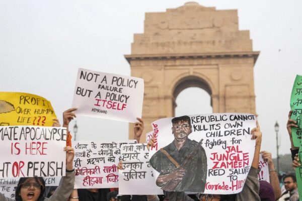 BJP leader Sudhanshu Trivedi criticized protesters at India Gate for raising slogans supporting a slain Naxal commander, accusing them of being influenced by “pollution of Marx and Mao.” The protest, initially against air pollution, saw demonstrators holding posters of Madvi Hidma, leading to arrests by Delhi Police for obstructing personnel and assaulting them.  NEW DELHI: Bharatiya Janata Party on Monday said that the “pollution of Marx and Mao” is denser in the brains of the agitators after slogans condemning Naxal commander Hidma’s encounter were raised during a protest over rising air pollution levels in Delhi.During a press conference, BJP leader Sudhanshu Trivedi said that the “real face” of protestors was out soon as they started raising slogans in support of a slain Naxal commander.”Some people reached India Gate with a mask on their faces that they are there to protest against the pollution. The masks were off as soon as they reached there, and the real face was out, and they started raising slogans in support of a slain Naxal commander,” the BJP leader said.He also latched on the incident to target Congress and claimed that the party “dreams” of coming to power with the support of the extremists.”The PM has said that the Congress has become the Muslim League-Maoist. More than the air pollution, the pollution of Marx and Mao is denser in their brains. Along with that, they dream of coming to power with the support of extremist ‘Kathmullas’. This is even more dangerous,” Trivedi said.This comes after visuals from the Sunday protest at India Gate showed the demonstrators holding posters of Maoist commander Madvi Hidma, who was recently killed in an encounter.”A protest was held this evening at C Hexagon, India Gate, over pollution. But the protesters were holding posters of Maoist commander Madvi Hidma. When they tried to block the road, the police tried to remove them, but they sprayed pepper spray on the police personnel and tried to attack them. The police are now taking legal action against them,” ANI quoted Delhi Police saying.Hidma, a CPI(M) central committee member and the secretary of the Dandakaranya Special Zonal Committee, was killed on November 18 along with his wife, Rajje, and four other Maoists in the Maredumilli forests of Andhra Pradesh’s Alluri Sitarama Raju district. Security forces had said the group initiated firing during a cordon-and-search operation, sparking an extended encounter.Meanwhile, Delhi Police also arrested 15 activist on charges of obstructing its personnel and assaulting them, besides blocking the road during the protest.Patiala House Court remanded 5 accused in 2 days’ judicial custody. The court has asked the police to file a copy of the videos in the court. Additionally, the court asked to send one accused to a safe house till his age is verified, as he has claimed to be a minor.The situation at the protest escalated as some demonstrators allegedly used pepper spray on police personnel while being removed from the scene, the official said.”The situation then turned into a scuffle, and some protesters used pepper spray on our personnel, which is unusual and rare,” the officer said, adding that so far, police have arrested at least 15 protesters.When asked about slogans allegedly raised in support of Maoist leader Madvi Hidma, the officer said they are probing the matter from all angles.The Delhi Coordination Committee for Clean Air, in a statement, said the city’s worsening air quality has become a “serious risk” to public health and alleged that authorities have failed to address the root causes of pollution.It further alleged that air quality has remained in the “severe” category, while the government relies on “cosmetic measures” such as water sprinklers, cloud seeding and spraying near Air Quality Index (AQI) stations instead of finding long-term solutions to tackle the issue.Meanwhile, Scientists for Society (SFS), one of the organisations that participated in Sunday’s “Delhi Against Clean Air” protest here, has distanced itself from certain groups that allegedly raised slogans unrelated to the protest’s central theme of air pollution.In a statement issued on Monday, the SFS said it had joined the protest “solely on the issue of pollution” and emphasised that the primary objective of the demonstration was to highlight Delhi’s severe air quality crisis, educate citizens, and question what they described as the government’s “failure and unwillingness” to act.About the AuthorTOI News DeskThe TOI News Desk comprises a dedicated and tireless team of journalists who operate around the clock to deliver the most current and comprehensive news and updates to the readers of The Times of India worldwide. With an unwavering commitment to excellence in journalism, our team is at the forefront of gathering, verifying, and presenting breaking news, in-depth analysis, and insightful reports on a wide range of topics. The TOI News Desk is your trusted source for staying informed and connected to the ever-evolving global landscape, ensuring that our readers are equipped with the latest developments that matter most.”Read MoreEnd of ArticleFollow Us On Social MediaVideos‘Enemies of the Nation Are Our Enemies’Owaisi Condemns Delhi Blast’Double Trade By 2030′: Piyush Goyal’s Big Remarks As India, Canada Agree To Resume FTA TalksTejas Crash: HAL Issues Clarification As Court Of Inquiry Probes Wing Commander Namansh Syal’s DeathDelhi Air Pollution Protest At India Gate Turns Violent Amid ‘Madvi Hidma Amar Rahe’ SlogansRajnath Singh’s Sindh Comment Sparks Pakistan Fury As Islamabad Labels India ‘Expansionist’ AgainINS Mahe Commissioned As Indian Navy’s New Aatmanirbhar Submarine Killer For Stronger Coastal ShieldSuicide Bombers Storm Pakistan’s FC Headquarters In Peshawar As Explosions Rock High-Security ZoneJustice Surya Kant, Known For Article 370 Ruling And Pegasus Scrutiny, Takes Oath As India’s New CJI’We May Have Run Away!’: Cyril Ramaphosa’s Joke To PM Modi on Hosting G20 Summit Sparks LaughterHow AQ Khan Became ‘Merchant Of Death’ And Triggered Musharraf’s Outrage, Reveals Ex CIA Operative123PhotostoriesFrom Dharmendra to Dev Anand: Veteran style icons who shaped Bollywood’s fashion historyFrom Nushrratt Bharuccha to Tiger Shroff: Bollywood stars stuck in repetitive on-screen images10 most effective natural hacks to permanently get rid of mice and rats at homeDelhi’s bold vision: Luxury metro coaches, tunnels and pod taxisSticking out: 8 animals with incredibly long tonguesAkshay Kumar’s discipline and fitness lessons for childrenSadhguru reveals how many times you must chew each bite for better digestionRemembering Dharmendra: Pall of gloom descends on Mumbai’s Sunny Villa, last rites performed at Vile Parle crematorium; celebrities, fans pay tributesWork picks up on Rs 621 crore Anna Salai flyover in Chennai as spans arrive10 phrases that can calm down an angry child123Hot PicksDelhi AQI TodayNew Labour CodeChennai rainGold rate todaySilver rate todayPublic Holidays NovemberBank Holidays NovemberTop TrendingNew Labour LawsIslam MakhachevCola Social Security PaymentsBrittany MahomesCanada Citizenship ActDelhi ProtestSmriti Mandhana WeddingJack HughesRama Raju MantenaFortnite Chapter 7 Leaked