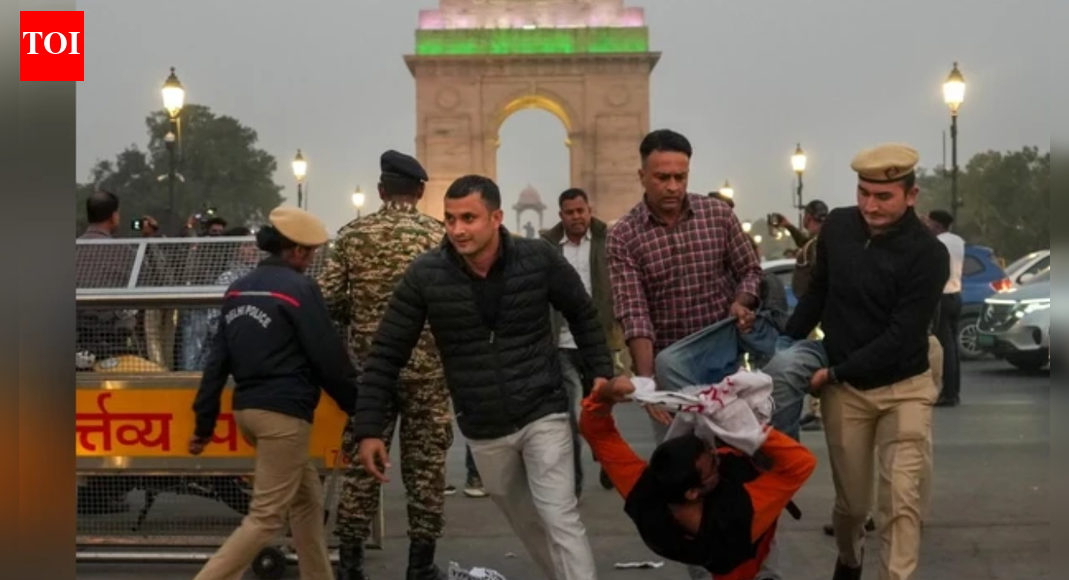 Seventeen protesters were sent to judicial custody in Delhi for demonstrating at India Gate against air pollution, bringing the total arrests to 22. Police reported protesters obstructed and assaulted officers, using pepper spray. Two FIRs were registered under the Bharatiya Nyaya Sanhita.  NEW DELHI: A Delhi court on Monday sent another 17 protesters to three-day judicial custody in connection with the November 23 demonstration at India Gate against rising air pollution levels, police said, as the total number of arrests linked to the protest rose to 22.Earlier today, Delhi Police arrested at least 15 people on charges of obstructing its personnel and assaulting them, besides blocking the road during a protest at the India Gate over rising air pollution levels in the national capital, an official told PTI. Officials said the group was detained for allegedly obstructing police personnel, assaulting them and blocking the road during the protest.Delhi Air Pollution Protest At India Gate Turns Violent Amid ‘Madvi Hidma Amar Rahe’ SlogansAccording to Delhi Police, two FIRs have been registered, one at Sansad Marg police station and another at Kartavya Path police station, under multiple sections of the Bharatiya Nyaya Sanhita, including those related to outraging the modesty of women.Police said the situation escalated on Sunday evening after a confrontation broke out while demonstrators were being removed from the site. “The situation then turned into a scuffle, and some protesters used pepper spray on our personnel, which is unusual and rare,” a police officer said. He added that the accused were produced before court on Monday.Authorities said the protest was held without permission at a non-designated site. “India Gate is not a designated protest site. The protesters were asked to leave. Jantar Mantar is the designated protest site, and anyone can demonstrate there after obtaining permission. On Sunday, the protesters blocked the C-Hexagon after jumping police barricades. They sat on the road for over an hour, and even people stuck in the traffic jam were requesting them to clear the way,” the officer said.He added that the protesters misbehaved with police. “Many police personnel sustained injuries during the scuffle and were rushed to RML Hospital for treatment. We are investigating the entire matter and checking CCTV footage to identify everyone involved,” he said.Police said they are also examining allegations that some protesters raised slogans in support of Maoist leader Madvi Hidma.Meanwhile, the Delhi Coordination Committee for Clean Air said the city’s worsening air quality has become a “serious risk” to public health. It alleged that the government is relying on “cosmetic measures” instead of addressing root causes, claiming PM2.5 levels have remained in the “severe” category.In a separate hearing, a Delhi court on Monday sent five students to two-day judicial custody in a related case registered at Kartavya Path police station over the alleged use of pepper spray on police officials during the protest. Judicial Magistrate Aridaman Singh Cheema also sent one accused to an observation home until age verification.The five students sent to judicial custody were identified as Akash, Ahan, Akshay, Sameer and Vishnu. Police have invoked sections 74, 115(2), 221 and 223 of the BNS for assault, causing hurt, obstruction of public servants and disobedience of lawful orders.About the AuthorTOI News DeskThe TOI News Desk comprises a dedicated and tireless team of journalists who operate around the clock to deliver the most current and comprehensive news and updates to the readers of The Times of India worldwide. With an unwavering commitment to excellence in journalism, our team is at the forefront of gathering, verifying, and presenting breaking news, in-depth analysis, and insightful reports on a wide range of topics. The TOI News Desk is your trusted source for staying informed and connected to the ever-evolving global landscape, ensuring that our readers are equipped with the latest developments that matter most.”Read MoreEnd of ArticleFollow Us On Social MediaVideos’Doesn’t Deserve LoP Post’: BJP Slams Rahul Gandhi For Missing CJI Surya Kant’s Oath CeremonyAs Pakistan Halts Afghan Transit, Kabul Boosts India Partnership And Fast-Tracks The Chabahar RouteIndia’s Soft Power Rises As Jaishankar Expands Global Gita Mahotsav, Kurukshetra Festival OutreachPunjab: Anandpur Sahib Hosts 3-Day Tribute on Guru Tegh Bahadur’s 350th Martyrdom Year’They Said Arunachal Is China’: Indian Woman Alleges Harassment After Passport Rejection In ShanghaiRajnath Says India Followed Krishna’s Message In Operation Sindoor After Pakistan Misread Decency‘Enemies of the Nation Are Our Enemies’Owaisi Condemns Delhi Blast’Double Trade By 2030′: Piyush Goyal’s Big Remarks As India, Canada Agree To Resume FTA TalksTejas Crash: HAL Issues Clarification As Court Of Inquiry Probes Wing Commander Namansh Syal’s DeathDelhi Air Pollution Protest At India Gate Turns Violent Amid ‘Madvi Hidma Amar Rahe’ Slogans123PhotostoriesThanksgiving side dishes: 5 easy recipes to try this yearA legend lives on: Nostalgic images of Dharmendra, the ‘He-Man’ of Bollywood10 Indian breakfasts that are high in protein and under 300 calories5 Indian baby name pairs that are perfect for siblingsDharmendra: The late legend’s heartwarming family picturesEvil Eye You Attract According To Your Date of BirthLong-term love tips: 8 practical ways to stay close and happy in a relationshipLate actor Dharmendra’s most touching parenting lessons: It’s all about love, simplicity and staying grounded10 winter getaways in India that double as European lookalikesPhotos and interesting facts from inside Bill Gates 5 Million home ‘Xanadu 2.0’123Hot PicksDelhi AQI TodayNew Labour CodeChennai rainGold rate todaySilver rate todayPublic Holidays NovemberBank Holidays NovemberTop TrendingNew Labour LawsIslam MakhachevCola Social Security PaymentsBrittany MahomesCanada Citizenship ActDelhi ProtestSmriti Mandhana WeddingJack HughesRama Raju MantenaFortnite Chapter 7 Leaked