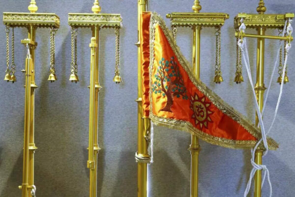 Prime Minister Narendra Modi has arrived in Ayodhya to hoist the specially crafted “Dharma Dhwaj” atop the Shri Ram Janmabhoomi Temple. This significant event, scheduled for Vivah Panchami during the auspicious Abhijit Muhurat, symbolizes the culmination of a centuries-old aspiration and a moment of immense cultural pride. The flag, engineered for durability, bears sacred symbols representing core Sanatan Dharma values. Ayodhya Dharma Dhawaj (PTI photo) NEW DELHI: Prime Minister Narendra Modi reached Ayodhya on Tuesday to hoist the “Dharma Dhwaj” atop the Shri Ram Janmabhoomi Temple, a moment residents describe as the fulfilment of a centuries-old aspiration.The specially designed flag, 22 feet long and 11 feet wide, has been crafted by a parachute specialist from Ahmedabad to withstand high-altitude conditions on the 161-foot temple summit. Weighing between two and three kilograms, the flag has been engineered for durability on the 42-foot flagpole.The ‘Dharma Dhwaj’ carries three sacred symbols, Om, the Sun and the Kovidara tree, each representing core values of Sanatan Dharma. Om signifies the eternal spiritual sound and cosmic vibration. The Sun symbol marks Lord Rama’s Suryavanshi lineage, invoking divine energy. The Kovidara tree, believed to be a hybrid of the Mandar and Parijat created by Rishi Kashyap, symbolises ancient knowledge and the continuity of sacred traditions.The flag is scheduled to be hoisted during the Abhijit Muhurat on Vivah Panchami, considered auspicious in the Ramayana tradition. A four-day ‘havan’ has been under way in the Yagna Mandap ahead of the ceremony, with around 100 priests performing rituals.Ram Janmabhoomi Teerth Kshetra general secretary Champat Rai said thousands of saints from eastern Uttar Pradesh and about 7,000 invitees will attend the ceremony. RSS chief Mohan Bhagwat, Uttar Pradesh hovernor and chief minister Yogi Adityanath are expected to be present. Mobile phones will not be permitted inside the temple premises during the event.Residents said the hoisting of the “Dharma Dhwaj” marks not only the completion of the Ram Temple’s construction but also a moment of cultural pride for followers of Sanatan Dharma around the world.About the AuthorTOI News DeskThe TOI News Desk comprises a dedicated and tireless team of journalists who operate around the clock to deliver the most current and comprehensive news and updates to the readers of The Times of India worldwide. With an unwavering commitment to excellence in journalism, our team is at the forefront of gathering, verifying, and presenting breaking news, in-depth analysis, and insightful reports on a wide range of topics. The TOI News Desk is your trusted source for staying informed and connected to the ever-evolving global landscape, ensuring that our readers are equipped with the latest developments that matter most.”Read MoreEnd of ArticleFollow Us On Social MediaVideosAsh Cloud From Ethiopia Hits India’s Airspace At High Speed, DGCA Issues Urgent Safety AdvisoryNew Tripura BSF IG Intensifies Border Vigilance Amid Bangladesh InstabilitySpectacular Tribute: 350th Martyrdom Day of Guru Tegh Bahadur Marked with Light-&-Sound ShowSecond Day of Guru Tegh Bahadur’s 350th Martyrdom Tribute Marked with Devotion in Punjab“Indian market offers smooth trade opportunities,” says ASSOCHAM Secretary‘Why? Why? Why?’ Mamata Slams EC, Flags ‘Unusual & Alarming’ Moves Ahead of Bengal Polls’Doesn’t Deserve LoP Post’: BJP Slams Rahul Gandhi For Missing CJI Surya Kant’s Oath CeremonyAs Pakistan Halts Afghan Transit, Kabul Boosts India Partnership And Fast-Tracks The Chabahar RouteIndia’s Soft Power Rises As Jaishankar Expands Global Gita Mahotsav, Kurukshetra Festival OutreachPunjab: Anandpur Sahib Hosts 3-Day Tribute on Guru Tegh Bahadur’s 350th Martyrdom Year123PhotostoriesBrain teaser for kids: Can you find 4 hidden faces in this image?10 things every teenage girl needs to know from her parentsMahabharat: Rare, unique and beautiful baby boy names inspired by the Indian epic5 signs your karma is finally clearing and blessings are nearEthiopia volcanic ash: How to explain this to your child (in simple way)7 foods that naturally warm the body7 ways to deal with an avoidant partnerDharmendra’s final curtain: A journey through his rarest unseen memoriesFind your life path number and understand what’s coming next in your lifeTop oncologist shares 5 foods that can help starve cancer and lower risk123Hot PicksDelhi AQI TodayNew Labour CodeCyclone SenyarGold rate todaySilver rate todayPublic Holidays NovemberBank Holidays NovemberTop TrendingTatsuya ImaiBlake LivelyJoe Thornton Net WorthStem OPT ExtensionMLB Trade RumorsTravis TurnerBrad MarchandTyson FuryDrake LondonDenver Nuggets vs Memphis Grizzlies