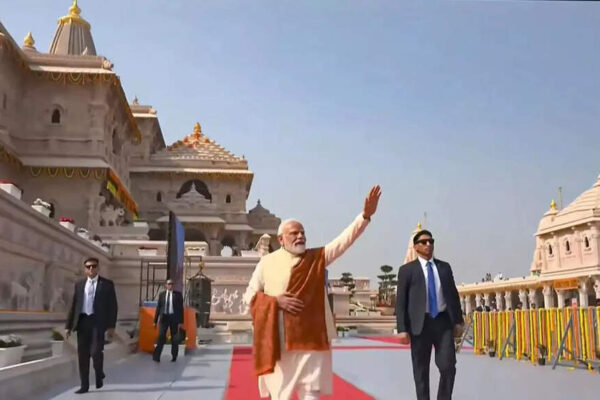 Prime Minister Narendra Modi ceremonially hoisted a saffron Dharma Dhwaj atop the Ram temple in Ayodhya, marking its formal construction completion. He stated that the ‘pain of centuries finds rest today’ and the resolve of centuries is attaining fulfillment. The flag symbolizes the renaissance of Indian civilisation and the ideals of Ram Rajya.  NEW DELHI: Prime Minister Narendra Modi on Tuesday said “the pain of centuries finds rest today” as he ceremonially hoisted a saffron “Dharma Dhwaj” atop the Ram temple in Ayodhya.Addressing the “Dharm Dhwaj Arohan Mahotsav” at Shri Ram Janmabhoomi Temple in Ayodhya, PM Modi said, “Today, the entire India and the world is Ram-may. There is extraordinary satisfaction in the heart of every Ram devotee. There is boundless gratitude. There is unfathomable supernatural bliss.””The pain of centuries finds rest today. The resolve of centuries is attaining fulfilment today. This is the completion of that sacred yajna whose flame remained lit for 500 years,” he added.PM Modi was joined by RSS chief Mohan Bhagwat, Uttar Pradesh Governor Anandiben Patel and chief minister Yogi Adityanath at the event.’Pain of centuries finds rest today’Addressing the gathering, Modi said, “Ayodhya is witnessing another epochal event in its history; entire country, globe is immersed in Ram.”He added, “The pain of centuries finds rest today. The resolve of centuries is attaining fulfilment today. This is the completion of that sacred yajna whose flame remained lit for five hundred years.”‘Ayodhya is emerging as backbone of a developed India’Modi said Ayodhya was reclaiming its place as a model for the world.”Today, Ayodhya is once again becoming that city which will serve as an example for the world. Ayodhya of the Treta Yuga gave humanity the gift of righteousness.””Ayodhya of the 21st century is giving humanity a new model of development. Then, Ayodhya was the centre of propriety. Now, Ayodhya is emerging as the backbone of a developed India.”He added that the future Ayodhya would reflect “a confluence of mythology and modernity,” where “the nectar-like flow of the Saryu River and the stream of development will flow together,” and “the harmony between spirituality and AI will be evident.”’Dharma Dhwaj is the banner of Indian civilisation’Modi described the flag as a symbol of struggle, devotion and civilisational resurgence.”This flag… is resolve, it is success! This flag… is the saga of creation born from struggle, the realised form of dreams carried through the centuries.””This Dharma Dhwaj is not merely a flag; it is the banner of the renaissance of Indian civilisation. Its saffron hue, the renown of the Solar Dynasty inscribed upon it, the depicted syllable Om, and the embossed Kovidara tree symbolise the glory of Ram Rajya.”He said the flag represented “the sacred outcome of the saints’ devotion and the collective participation of society” and would, for generations, proclaim the ideals of Lord Ram.Temples built for key figures of the RamayanaPM Modi highlighted the seven temples built within the complex, including those dedicated to Mata Shabari, Nishadraj, Maa Ahilya, Maharishi Valmiki, Maharishi Vashishtha, Maharishi Vishwamitra, Maharishi Agastya and Sant Tulsidas.Statues of Jatayu and the Gilehri, he said, symbolise the value of every contribution “however small, for the fulfilment of great resolutions.”‘Ayodhya is the land where ideals become conduct’Calling Ayodhya the city that shaped Lord Ram’s journey, PM Modi said it taught the world how a person “rises to become ‘Maryada Purushottam’.””This Dharmadhwaj shall serve as an inspiration: that life may depart, but the word must not… This Dharmadhwaj shall convey the message—Karmapradhan vishwa rachi rakha.”He said the flag aspired to a society free of “discrimination, suffering, and distress,” bringing “peace and happiness.” The whole world will be run by that flag: Bhagwat Addressing a large gathering in the presence of PM Modi, Yogi Adityanath, and thousands of attendees, RSS chief Mohan Bhagwat called the occasion a “significant day for all”. He began by expressing gratitude and recalled the decades-long Ram Mandir movement, honouring those who dreamt, struggled, and sacrificed their lives for the cause. “Numerous people saw a dream, numerous people made efforts, and numerous people made sacrifices. Their souls must be full today,” he said, adding that, “Ashok ji (Ashok Singhal) must have felt peace today. Mahant Ram Chandra Das ji Maharaj, Dalmia ji (senior VHP leader Vishnu Hari Dalmia) and numerous saints, people and students sacrificed their lives and worked hard.”Bhagwat described the ceremonial flag unfurled at the temple as a symbol of the legacy of Ram Rajya — a vision of justice, peace and prosperity. “The ‘dhwaj’ of Ram Rajya, which once flew high in Ayodhya and used to spread peace and prosperity to the world, is now seated at its ‘shikhar’ and we witnessed this happening,” he said, calling the moment spiritually meaningful.He stressed that the moment was not just symbolic but deeply spiritual. “‘Bhagwa’ is the colour of this flag, it is ‘Dharmdhwaj’. The whole world will be run by that flag,” he declared.’A new era for the nation’Further chief minister Yogi Adityanath said the saffron flag marked the beginning of a “new era” for the nation, asserting that the Ram Temple stands as a symbol of the faith and self-respect of 140 crore Indians. Recalling the long struggle, he said the Ram Janmabhoomi movement had only one slogan, ‘Ram Lalla hum aayenge. Mandir wahin banayenge. Lathi goli khayenge, mandir wahin banayenge”.The triangular flag, measuring 10 feet by 20 feet, features a radiant Sun, the sacred ‘Om’, and the Kovidara tree. It was hoisted during the “Abhijit Muhurat,” considered highly auspicious.Champat Rai, general secretary of the Shri Ram Janmabhoomi Teerth Kshetra, said the ceremony marked the formal completion of the temple’s construction. He said the saffron colour symbolises “fire and the rising sun — representing sacrifice and dedication.”About the AuthorTOI News DeskThe TOI News Desk comprises a dedicated and tireless team of journalists who operate around the clock to deliver the most current and comprehensive news and updates to the readers of The Times of India worldwide. With an unwavering commitment to excellence in journalism, our team is at the forefront of gathering, verifying, and presenting breaking news, in-depth analysis, and insightful reports on a wide range of topics. The TOI News Desk is your trusted source for staying informed and connected to the ever-evolving global landscape, ensuring that our readers are equipped with the latest developments that matter most.”Read MoreEnd of ArticleFollow Us On Social MediaVideosDiplomatic Row Explodes After China Rejects Arunachal Woman’s Passport During Shanghai Transit HaltAsh Cloud From Ethiopia Hits India’s Airspace At High Speed, DGCA Issues Urgent Safety AdvisoryNew Tripura BSF IG Intensifies Border Vigilance Amid Bangladesh InstabilitySpectacular Tribute: 350th Martyrdom Day of Guru Tegh Bahadur Marked with Light-&-Sound ShowSecond Day of Guru Tegh Bahadur’s 350th Martyrdom Tribute Marked with Devotion in Punjab“Indian market offers smooth trade opportunities,” says ASSOCHAM Secretary‘Why? Why? Why?’ Mamata Slams EC, Flags ‘Unusual & Alarming’ Moves Ahead of Bengal Polls’Doesn’t Deserve LoP Post’: BJP Slams Rahul Gandhi For Missing CJI Surya Kant’s Oath CeremonyAs Pakistan Halts Afghan Transit, Kabul Boosts India Partnership And Fast-Tracks The Chabahar RouteIndia’s Soft Power Rises As Jaishankar Expands Global Gita Mahotsav, Kurukshetra Festival Outreach123PhotostoriesFrom being independent to living life on her own terms: Neena Gupta’s 5 bold statements on motherhoodPunjabi aa gaye oye! Diljit Dosanjh sets the Emmys 2025 red carpet on fireKnow the things you must strictly avoid according to your birth dateAnanya Panday turns heads in one of the season’s most striking saree gown looks10 things every teenage boy needs to know from their parentsIs your cat scared of guests or secretly curious? How to read the signalsBrain teaser for kids: Can you find 4 hidden faces in this image?10 things every teenage girl needs to know from her parentsMahabharat: Rare, unique and beautiful baby boy names inspired by the Indian epic5 signs your karma is finally clearing and blessings are near123Hot PicksDelhi AQI TodayNew Labour CodeCyclone SenyarGold rate todaySilver rate todayPublic Holidays NovemberBank Holidays NovemberTop TrendingEthiopian Volcanic EruptionVaishno Devi College AdmissionsStephen CurryJoe Thornton Net WorthStem OPT ExtensionMLB Trade RumorsTravis TurnerAsha Jadeja MotwaniTyson FuryTrump Gold Card