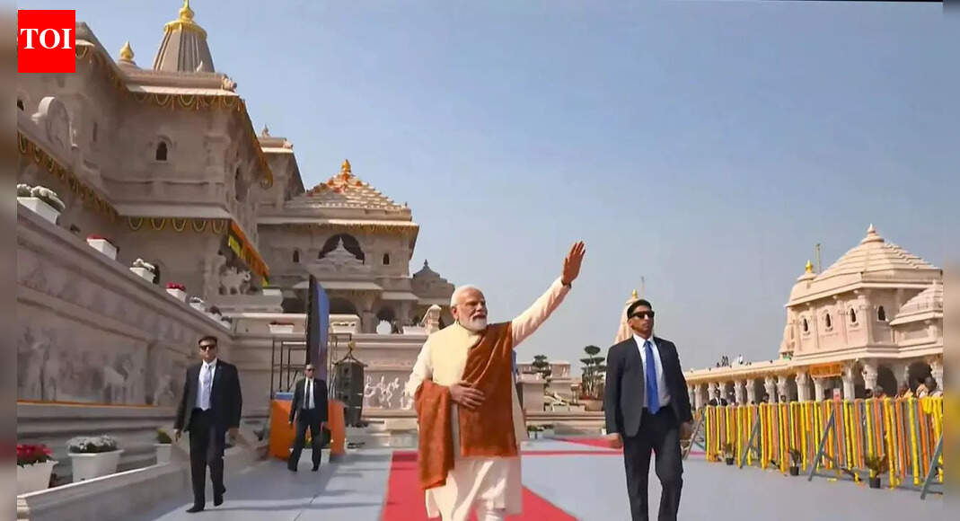 Prime Minister Narendra Modi ceremonially hoisted a saffron Dharma Dhwaj atop the Ram temple in Ayodhya, marking its formal construction completion. He stated that the ‘pain of centuries finds rest today’ and the resolve of centuries is attaining fulfillment. The flag symbolizes the renaissance of Indian civilisation and the ideals of Ram Rajya.  NEW DELHI: Prime Minister Narendra Modi on Tuesday said “the pain of centuries finds rest today” as he ceremonially hoisted a saffron “Dharma Dhwaj” atop the Ram temple in Ayodhya.Addressing the “Dharm Dhwaj Arohan Mahotsav” at Shri Ram Janmabhoomi Temple in Ayodhya, PM Modi said, “Today, the entire India and the world is Ram-may. There is extraordinary satisfaction in the heart of every Ram devotee. There is boundless gratitude. There is unfathomable supernatural bliss.””The pain of centuries finds rest today. The resolve of centuries is attaining fulfilment today. This is the completion of that sacred yajna whose flame remained lit for 500 years,” he added.PM Modi was joined by RSS chief Mohan Bhagwat, Uttar Pradesh Governor Anandiben Patel and chief minister Yogi Adityanath at the event.’Pain of centuries finds rest today’Addressing the gathering, Modi said, “Ayodhya is witnessing another epochal event in its history; entire country, globe is immersed in Ram.”He added, “The pain of centuries finds rest today. The resolve of centuries is attaining fulfilment today. This is the completion of that sacred yajna whose flame remained lit for five hundred years.”‘Ayodhya is emerging as backbone of a developed India’Modi said Ayodhya was reclaiming its place as a model for the world.”Today, Ayodhya is once again becoming that city which will serve as an example for the world. Ayodhya of the Treta Yuga gave humanity the gift of righteousness.””Ayodhya of the 21st century is giving humanity a new model of development. Then, Ayodhya was the centre of propriety. Now, Ayodhya is emerging as the backbone of a developed India.”He added that the future Ayodhya would reflect “a confluence of mythology and modernity,” where “the nectar-like flow of the Saryu River and the stream of development will flow together,” and “the harmony between spirituality and AI will be evident.”’Dharma Dhwaj is the banner of Indian civilisation’Modi described the flag as a symbol of struggle, devotion and civilisational resurgence.”This flag… is resolve, it is success! This flag… is the saga of creation born from struggle, the realised form of dreams carried through the centuries.””This Dharma Dhwaj is not merely a flag; it is the banner of the renaissance of Indian civilisation. Its saffron hue, the renown of the Solar Dynasty inscribed upon it, the depicted syllable Om, and the embossed Kovidara tree symbolise the glory of Ram Rajya.”He said the flag represented “the sacred outcome of the saints’ devotion and the collective participation of society” and would, for generations, proclaim the ideals of Lord Ram.Temples built for key figures of the RamayanaPM Modi highlighted the seven temples built within the complex, including those dedicated to Mata Shabari, Nishadraj, Maa Ahilya, Maharishi Valmiki, Maharishi Vashishtha, Maharishi Vishwamitra, Maharishi Agastya and Sant Tulsidas.Statues of Jatayu and the Gilehri, he said, symbolise the value of every contribution “however small, for the fulfilment of great resolutions.”‘Ayodhya is the land where ideals become conduct’Calling Ayodhya the city that shaped Lord Ram’s journey, PM Modi said it taught the world how a person “rises to become ‘Maryada Purushottam’.””This Dharmadhwaj shall serve as an inspiration: that life may depart, but the word must not… This Dharmadhwaj shall convey the message—Karmapradhan vishwa rachi rakha.”He said the flag aspired to a society free of “discrimination, suffering, and distress,” bringing “peace and happiness.” The whole world will be run by that flag: Bhagwat Addressing a large gathering in the presence of PM Modi, Yogi Adityanath, and thousands of attendees, RSS chief Mohan Bhagwat called the occasion a “significant day for all”. He began by expressing gratitude and recalled the decades-long Ram Mandir movement, honouring those who dreamt, struggled, and sacrificed their lives for the cause. “Numerous people saw a dream, numerous people made efforts, and numerous people made sacrifices. Their souls must be full today,” he said, adding that, “Ashok ji (Ashok Singhal) must have felt peace today. Mahant Ram Chandra Das ji Maharaj, Dalmia ji (senior VHP leader Vishnu Hari Dalmia) and numerous saints, people and students sacrificed their lives and worked hard.”Bhagwat described the ceremonial flag unfurled at the temple as a symbol of the legacy of Ram Rajya — a vision of justice, peace and prosperity. “The ‘dhwaj’ of Ram Rajya, which once flew high in Ayodhya and used to spread peace and prosperity to the world, is now seated at its ‘shikhar’ and we witnessed this happening,” he said, calling the moment spiritually meaningful.He stressed that the moment was not just symbolic but deeply spiritual. “‘Bhagwa’ is the colour of this flag, it is ‘Dharmdhwaj’. The whole world will be run by that flag,” he declared.’A new era for the nation’Further chief minister Yogi Adityanath said the saffron flag marked the beginning of a “new era” for the nation, asserting that the Ram Temple stands as a symbol of the faith and self-respect of 140 crore Indians. Recalling the long struggle, he said the Ram Janmabhoomi movement had only one slogan, ‘Ram Lalla hum aayenge. Mandir wahin banayenge. Lathi goli khayenge, mandir wahin banayenge”.The triangular flag, measuring 10 feet by 20 feet, features a radiant Sun, the sacred ‘Om’, and the Kovidara tree. It was hoisted during the “Abhijit Muhurat,” considered highly auspicious.Champat Rai, general secretary of the Shri Ram Janmabhoomi Teerth Kshetra, said the ceremony marked the formal completion of the temple’s construction. He said the saffron colour symbolises “fire and the rising sun — representing sacrifice and dedication.”About the AuthorTOI News DeskThe TOI News Desk comprises a dedicated and tireless team of journalists who operate around the clock to deliver the most current and comprehensive news and updates to the readers of The Times of India worldwide. With an unwavering commitment to excellence in journalism, our team is at the forefront of gathering, verifying, and presenting breaking news, in-depth analysis, and insightful reports on a wide range of topics. The TOI News Desk is your trusted source for staying informed and connected to the ever-evolving global landscape, ensuring that our readers are equipped with the latest developments that matter most.”Read MoreEnd of ArticleFollow Us On Social MediaVideosDiplomatic Row Explodes After China Rejects Arunachal Woman’s Passport During Shanghai Transit HaltAsh Cloud From Ethiopia Hits India’s Airspace At High Speed, DGCA Issues Urgent Safety AdvisoryNew Tripura BSF IG Intensifies Border Vigilance Amid Bangladesh InstabilitySpectacular Tribute: 350th Martyrdom Day of Guru Tegh Bahadur Marked with Light-&-Sound ShowSecond Day of Guru Tegh Bahadur’s 350th Martyrdom Tribute Marked with Devotion in Punjab“Indian market offers smooth trade opportunities,” says ASSOCHAM Secretary‘Why? Why? Why?’ Mamata Slams EC, Flags ‘Unusual & Alarming’ Moves Ahead of Bengal Polls’Doesn’t Deserve LoP Post’: BJP Slams Rahul Gandhi For Missing CJI Surya Kant’s Oath CeremonyAs Pakistan Halts Afghan Transit, Kabul Boosts India Partnership And Fast-Tracks The Chabahar RouteIndia’s Soft Power Rises As Jaishankar Expands Global Gita Mahotsav, Kurukshetra Festival Outreach123PhotostoriesFrom being independent to living life on her own terms: Neena Gupta’s 5 bold statements on motherhoodPunjabi aa gaye oye! Diljit Dosanjh sets the Emmys 2025 red carpet on fireKnow the things you must strictly avoid according to your birth dateAnanya Panday turns heads in one of the season’s most striking saree gown looks10 things every teenage boy needs to know from their parentsIs your cat scared of guests or secretly curious? How to read the signalsBrain teaser for kids: Can you find 4 hidden faces in this image?10 things every teenage girl needs to know from her parentsMahabharat: Rare, unique and beautiful baby boy names inspired by the Indian epic5 signs your karma is finally clearing and blessings are near123Hot PicksDelhi AQI TodayNew Labour CodeCyclone SenyarGold rate todaySilver rate todayPublic Holidays NovemberBank Holidays NovemberTop TrendingEthiopian Volcanic EruptionVaishno Devi College AdmissionsStephen CurryJoe Thornton Net WorthStem OPT ExtensionMLB Trade RumorsTravis TurnerAsha Jadeja MotwaniTyson FuryTrump Gold Card