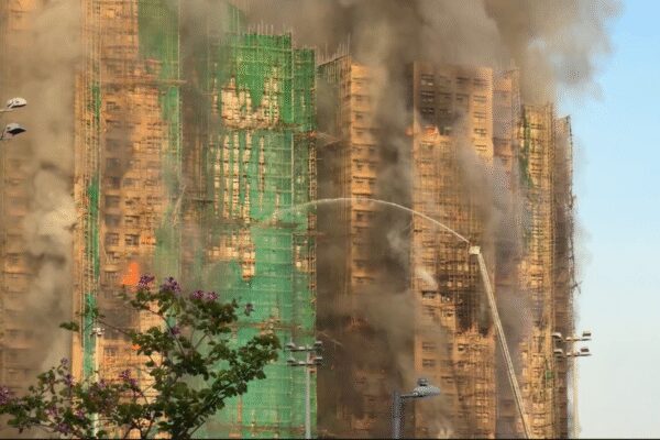 Massive fire engulfs multiple high rises in Hong Kong; at least 4 dead – video