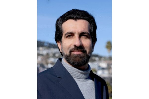 Why was an Iranian professor on H-1B visa detained by ICE?