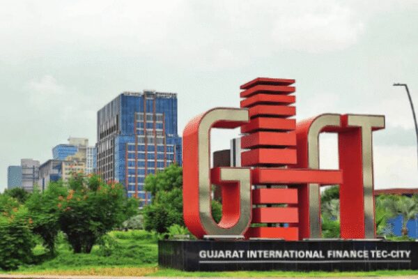 It’s been about two years since GIFT City — the financial hub near Ahmedabad — began serving alcohol. As patrons gradually pour in, officials say it’s an apt model that balances prohibition and the need to attract a more globalised workforce – When Gujarat lifted its prohibition laws within GIFT City on New Year’s Eve 2023, it made national headlines. For a state where ‘dry’ has been a foundational principle since 1960, the move to create a watering hole where professionals could socialise — even if within the perimeters of India’s first international financial hub — felt audacious.Two years later, the glass remains half full, measured rather than overflowing. Official figures show 985 permanent employees with liquor access permits and 5,291 temporary ones for visitors. With 5,552 bulk litres of liquor sold to date — a modest but telling figure — Gujarat’s experiment with controlled conviviality proves that even in prohibition territory, business pragmatism can find a way.Policy To PracticeInside GIFT City, every drink has a paper trail. Gujarat’s first taste of legal liquor operates within one of the most controlled ecosystems in the country: precise, trackable and fenced in by policy.Only those employed with registered firms in GIFT City can raise a glass — and only after securing a two-year access permit, renewable for Rs 1,000 annually. Visitors can join in, but only through one-day temporary permits issued by an authorised recommending officer.Each permit holder is allowed to host up to five guests at a time within licensed ‘wine and dine’ zones — sealed-off spaces inside hotels, clubs and restaurants operating under a designated foreign liquor licence. While there is no official limit on consumption volume, everything is billed and recorded.Even with a valid permit, the glass must stay within these designated zones. Every guest’s name is registered before service, every bill traceable, and yes, even Ahmedabad residents can be invited, provided the meeting is deemed business-related. The guardrails extend beyond the bar counter. Those who drink cannot drive; they must leave with a designated driver. In case of an inquiry, a wine-and-dine bill serves as proof of authorised consumption — every toast documented in detail within Gujarat’s carefully calibrated social experiment.Going With The FlowGIFT City’s social scene operates within tight boundaries. Currently, two wine-and-dine facilities serve the zone, with more planned as new commercial towers and hotels open.Taral Shah, a developer working on projects in GIFT City, said: “GIFT City is India’s only operational International Financial Services Centre (IFSC) and smart city, and we have seen interest growing among foreign companies year by year. With liquor norms relaxed, companies from Delhi, Mumbai and Bengaluru are also setting up base in GIFT City. We expect more facilities as additional buildings become operational. We also hope that taxes will come down because wine-anddine facilities here primarily serve the salaried class. When the govt announced the relaxation two years ago, real estate enquiries in GIFT City saw a sudden jump of 25-30%.”- The impact extends beyond realty metrics. An official at one of the licensed wine-and-dine facilities said the relaxation has transformed the sentiment within GIFT City: more employees now stay back in the evenings to catch up over drinks.“On weekdays, we see an average of about 15 people coming in to wine and dine. The number doubles to around 30 on weekends. The VAT is higher than other states, but we expect it to be rationalised soon and brought on a par with other states, which should further drive consumption,” the official said.The shift is reshaping the everyday rhythm at GIFT City as professionals embrace post-work socialisation. “The relaxation of liquor laws is a welcome move. The process of obtaining access is also convenient and easy. GIFT City is successfully creating a lifestyle and culture that matches international standards,” said Dhruv Singh (name changed), a professional working at GIFT City. Small changes signal larger shifts. Earlier, photography was banned at these facilities, but that restriction has been lifted — suggesting that GIFT City is easing into its new culture of controlled comfort.Choice Of DrinksThe demographics tell their own story: 15% of visitors at GIFT City’s wine-and-dine facilities are foreigners, while 85% are Indian, primarily employees and their occasional guests. The typical patron is between 26 and 45 years old. Beer dominates, with most patrons preferring to unwind over a pint or light drink after work. Spirits see lower uptake, likely due to both preferences and higher taxation.The licensed facilities operate from 11am and attract some daytime visitors, too, though crowds peak in the evenings. “We’re also seeing small groups using the space for formal and informal business discussions,” said a hotelier.Corporate CautionNot every company, however, is ready to raise a toast just yet. Some firms deliberately avoid issuing permission letters for employees to access these facilities.“Our organisation has made a conscious decision to not issue letters to employees for drinking at the wine-and-dine facilities at GIFT City. Since alcohol prohibition continues beyond GIFT City limits, companies are worried about any incident that could tarnish their reputation,” explains Tanya Sharma (name changed), who works with an MNC at GIFT-IFSC.Hospitality PotentialIndustry leaders see broader potential. Narendra Somani, president of the Hotels and Restaurants’ Association (HRA), Gujarat, argues that two years of regulated liquor access at GIFT City shows how controlled liberalisation can help build a wineand-dine culture while also generating revenue for the state. – “Govt should consider extending such relaxations in a regulated manner across Gujarat, especially with increasing foreign investments in Ahmedabad, a growing expat community, and Gujarat’s bids for the Commonwealth Games 2030 [which it won on Wednesday] and the 2036 Olympics. Gujarat’s hospitality sector loses social and corporate event business to other states. With thoughtful liberalisation, Gujarat’s tourism industry could take a significant leap forward,” Somani said.‘Global Readiness’Sanjay Kaul, IAS, MD and group CEO, GIFT City, said: “The streamlining of prohibition norms specific to GIFT City has been widely welcomed by companies and professionals, who see it as a reflection of the city’s global readiness.”The numbers may appear modest, but they represent Gujarat’s incremental approach to social liberalisation within an economic enclave, carefully avoiding any challenge to the broader prohibition framework across the state.- A senior official emphasises that the relaxation aligns with GIFT City’s ambition to position itself as a global financial hub.“Several companies in GIFT City had identified prohibition as a challenge in attracting young talent. Since the relaxation, we have growing traction from global firms and multinational corporations. Previously, semiconductor design companies favoured Bengaluru or Hyderabad. But now, with a semiconductor manufacturing cluster coming up in Gujarat, GIFT City has become a viable alternative,” a GIFT City official said.Recent developments support this claim. Sources confirmed that a European semiconductor design firm recently established an office in GIFT City. “Global corporations require wine-and-dine facilities not just for employees but also for hosting international clients. With world-class infrastructure, airport connectivity, and the recent easing of liquor norms, GIFT City now stands on a par with other global financial hubs,” the official added.Larger QuestionGIFT City’s liquor model remains unique: a closed-loop ecosystem where access, sale, and consumption are all verified and logged — an administrative “wet bubble” in an otherwise dry state.As GIFT City expands with new corporate tenants and residential projects, the central question persists: will Gujarat replicate this model elsewhere, or will it remain a singular concession at India’s global financial hub?For now, Gujarat’s controlled experiment continues — each glass raised within GIFT City represents not just a drink, but a data point in one of India’s most closely-watched policy experiments.About the AuthorTOI News DeskThe TOI News Desk comprises a dedicated and tireless team of journalists who operate around the clock to deliver the most current and comprehensive news and updates to the readers of The Times of India worldwide. With an unwavering commitment to excellence in journalism, our team is at the forefront of gathering, verifying, and presenting breaking news, in-depth analysis, and insightful reports on a wide range of topics. The TOI News Desk is your trusted source for staying informed and connected to the ever-evolving global landscape, ensuring that our readers are equipped with the latest developments that matter most.”Read MoreEnd of ArticleFollow Us On Social MediaVideosPM Modi Predicts India’s Global Dominance In Satellite Launches As Skyroot Unveils Vikram-I RocketBJP Slams Pakistan Over Ram Temple Remarks, Says Lecturing India Mirrors Osama-Like HypocrisyDelhi: Industrialist’s Daughter-In-Law Found Dead In Vasant Vihar, Diary Mentions ‘Love And Trust’Dhaka Slum Inferno Leaves Thousands Homeless As 1,500 Shanties Collapse Into Ash And Twisted RubbleNepal: Dhangadhi Tense As KP Oli-Led CPN-UML Cadres Clash With Gen-Z Youths, 2nd Incident In A WeekMEA Clears Air On Putin’s India Visit Dates As Both Nations Prepare For High-Stake Strategic Summit“Being Examined”: MEA On Dhaka’S Request To Extradite Sheikh Hasina”There Was No Fear on His Face”: Survivor Recounts Trauma of Mumbai 26/11 AttacksPakistan On Edge As Imran Khan’s Sisters Assaulted At Jail And Social Media Fuels Death Speculation’Spur Of The Moment’: Former CJI Gavai Reacts To Shoe-Attack Attempt, Reveals Why He Took No Action123PhotostoriesRama Raju Mantena: Rare photos of the man everyone is searching forWhy airplane windows have a tiny holeFrom Saira Banu, Shah Rukh Khan to Amitabh Bachchan: How B-town paid emotional tribute to the evergreen DharmendraWhat happens to the body when you stop eating carbohydrates?Cute Indian names for baby girls born on ThursdayTwin pregnancy: Early signs you might be carrying twins; what moms might notice firstEveryone thinks it’s the pregnant lady: Can you solve this watermelon heist mystery?8 diabetic-friendly sweet fruits that have a low glycemic indexHong Kong tower blaze: How the tragedy unfolded – Visual guideYour Protective Guardian Angel According To Your Date of Birth123Hot PicksDelhi AQI TodayNew Labour CodeWorld NewsGold rate todaySilver rate todayPublic Holidays NovemberBank Holidays NovemberTop TrendingDeion SandersAyesha CurryTaylor SwiftMarqury CollinsStefon DiggsSaudi Prince Mohammed Bin SalmanCharlie McAvoyPaige SpiranacSteveWillDoIt ControversyCandace Owens