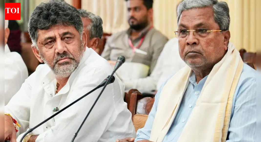 Karnataka’s top Congress leaders, chief minister Siddaramaiah and deputy CM DK Shivakumar, engaged in a public spat on social media. Shivakumar alluded to a “secret deal” for a rotational chief ministership, while Siddaramaiah countered by emphasizing his commitment to a full five-year term and highlighting fulfilled promises. This open conflict signals a significant escalation beyond their supporters’ verbal exchanges.  NEW DELHI: The power tussle for the top post in Karnataka Congress turned ugly on Thursday with chief minister Siddaramaiah taking open potshots at his deputy DK Shivakumar. Hours after Shivakumar posted a cryptic message reminding Siddaramaiah and the Congress high command to “keep one’s word and walk the talk”, the chief minister has hit back using “word play” to target his deputy. Earlier today, Shivakumar in a post on X wrote, “WORD POWER IS WORLD POWER. The biggest force in the world is to keep one’s word. Be it a judge, president or anyone else including myself, everyone has to walk the talk. Word power is world power.” The state Congress president, who is eyeing the top post as part of a “secret deal” in 2023 for rotational CM following the party’s sweeping victory in the assembly elections, wants Siddaramaiah to honour the commitment made then by the party leadership.’All 140 MLAs Are Mine’: DK Shivakumar Amid Karnataka CM Speculation; Siddaramaiah Responds Siddaramaiah, who has often asserted that he will complete his term of 5 years, made an interesting response to DKS message. The chief minister used the same words to take potshots at his deputy. “A Word is not power unless it betters the World for the people. The mandate given by the people of Karnataka is not a moment, but a responsibility that lasts five full years. The Congress party, including me, is walking the talk for our people with compassion, consistency, and courage. Our Word to Karnataka is not a slogan, it means the World to us,” Siddaramaiah wrote on X.Siddaramaiah then went on to list the promises that he had fulfilled as the chief minister in his two tenures. This open social media “word” war between the two top state leaders marks a definite shift in their approach. Till now, it was the supporters of the two leaders who were engaging in verbal spats. But with Siddaramaiah completing two-and-a-half years as chief minister, DKS has clearly upped the ante. The ball is in the court of Congress high command, but the open spat between the two leaders could well damage the prospects of the grand-old-party even if it manages to save its government for now.About the AuthorTOI News DeskThe TOI News Desk comprises a dedicated and tireless team of journalists who operate around the clock to deliver the most current and comprehensive news and updates to the readers of The Times of India worldwide. With an unwavering commitment to excellence in journalism, our team is at the forefront of gathering, verifying, and presenting breaking news, in-depth analysis, and insightful reports on a wide range of topics. The TOI News Desk is your trusted source for staying informed and connected to the ever-evolving global landscape, ensuring that our readers are equipped with the latest developments that matter most.”Read MoreEnd of ArticleFollow Us On Social MediaVideosOusted PM Sheikh Hasina Faces Fresh Conviction as Court Awards 21-Year TermPM Modi Announces Major Move Allowing Private Players Into Nuclear Sector To Spur Advanced ReactorsExplained: Why Vikram-I Could Transform India’s Satellite Launch Market And Global Space Leadership‘Pak, Bangladesh, US…’: BJP Alleges Congress Using Foreign ‘X’ Accounts to Set India’s NarrativePakistan’s Adiala Jail Issues Statement On Imran Khan’s Health Amid Viral Death RumoursThe Indrajaal Ranger: India Unveils AI-Enabled Anti-Drone Patrol Vehicle In HyderabadBrahMos Diplomacy Peaks As Rajnath Singh Deepens India-Indonesia Defence Ties In Indo-Pacific ShiftOperation Sindoor Showed India’s Strength, Discipline And Deterrence To The World: President Murmu’Years Of Reforms & Readiness Translated Into Decisive Outcomes In Op Sindoor’: Army Chief DwivediPM Modi Predicts India’s Global Dominance In Satellite Launches As Skyroot Unveils Vikram-I Rocket123Photostories10 unique seven-letter baby names loved by new parentsHow to make South Indian-Style Beetroot Poha for BreakfastSigns that Shani is Upset With You10 affordable date ideas that help you bond without spending much5 places in the world you can’t set foot in — and whyInside the glamorous world of Manish Malhotra’s Bandra bungalowBaby names that are banned in the USBruce Lee’s birthday: Ten fun facts you didn’t know about the Little DragonStranger Things kids growing up; Find out their real ages in 2025!Decoding Keerthy Suresh’s best rush-hour fashion looks for ‘Revolver Rita’ promotions | See pics123Hot PicksDelhi AQI TodayNew Labour CodeWorld NewsGold rate todaySilver rate todayPublic Holidays NovemberBank Holidays NovemberTop TrendingDeion SandersAyesha CurryTaylor SwiftMarqury CollinsStefon DiggsSaudi Prince Mohammed Bin SalmanCharlie McAvoyWPL Auction Who Got WhomSteveWillDoIt ControversyCandace Owens