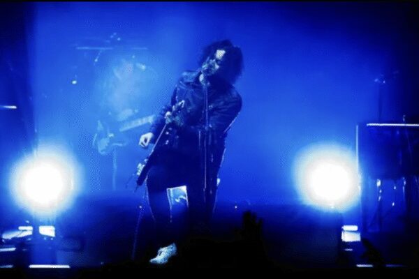 Who is Jack White performing with Eminem at the Packers-Lions Thanksgiving halftime?