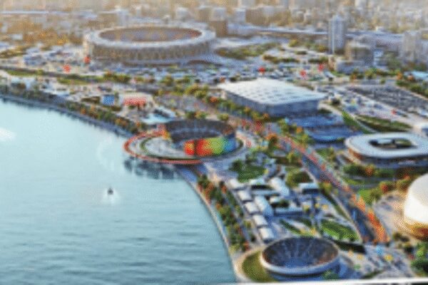 As it gets ready to host the 2030 Commonwealth Games, the city has one eye on the 2036 Olympic Games bid. Fuelling it all are infrastructure projects designed to make it the ‘sports capital’ of India . Confirmation of Ahmedabad as the host city for the 2030 Commonwealth Games (CWG) has sounded the starting gun for an accelerated infrastructure race across the Ahmedabad-Gandhinagar belt. The Commonwealth Sport General Assembly’s approval on Wednesday has pushed the twin cities into delivery mode, with officials stressing that major venue construction plans are locked into a firm timeline.Speaking to the media in Glasgow after Ahmedabad won hosting rights, Gujarat principal secretary (sports, youth and cultural activities) Ashwani Kumar said that the city is poised to be the sports capital of India. “The construction of the Sardar Vallabhbhai Patel Sports Enclave (SVPSE) and the Police Academy Sports Hub will begin in April 2026 and finish by late 2028 or early 2029,” he said..He announced that funding for both these projects had been secured by the govt and that “most venues for the 2030 Games are ready”. He also said that the “organising committee will be constituted within a month”.Long-term visionMuch of the Games’ footprint will be centred on the SVPSE — a purpose-built zone that will anchor Gujarat’s longterm sporting ecosystem. The enclave will house an arena, aquatic centre, tennis courts, training zones, and athlete villages. The Karai Police Academy complex will host athletics, shooting and other disciplines. For Gujarat, the CWG is as much about global visibility as about creating infrastructural and sporting capacity that endures beyond 2030..Unlike some sporting meets that span multiple states, the 2030 Games will be strikingly compact, concentrated almost entirely within the Ahmedabad-Gandhinagar cluster. That will enable faster movement and a lower carbon footprint. “This compactness cuts athlete travel time and allows seamless integration of metro, BRTS and electric mobility,” states the document, ‘Games Vision, Concept and Legacy — Commonwealth Games 2030’, presented before the CWG committee. Only two disciplines — cycling at the Statue of Unity (near Kevadia) and women’s cricket in Vadodara — will take place outside this hub.The Narendra Modi Stadium, the world’s largest cricket stadium, will host the opening and closing ceremonies of the 2030 Games — massive productions that are expected to reflect the Commonwealth Sport values.Beyond the Games, Gujarat — which hosted the National Games in 2022 — is pushing lesser-known disciplines like netball, lawn bowls, kabaddi, and yogasana into the spotlight. The bigger shift is strategic — Ahmedabad and Gandhinagar aim to become year round sports cities, with high performance labs, community spaces and university-linked infrastructure to ensure post Games utilisation..Focus on sustainabilityAhmedabad also plans to discuss sustainability, diversity and inclusion during the Commonwealth heads of govt meeting (CHOGM) 2026 and 2028.Tejas Joshi, president of Credai Gujarat, said, “Hosting the CWG will be a game changer for Ahmedabad. The city’s infrastructure will see a drastic change with improved roads and connectivity. It will create demand for around 20,000 star-category hotel rooms and boost hotel and retail development. It will also eventually bring new migration to the city, resulting in increased housing demand.”Accommodation is expanding fast. “Ahmedabad and Gandhinagar offer 5,420 hotel rooms in the 3-5 star range, with 3,000 more planned, including 1,500 new 5-star rooms. Upgraded university hostels will house athletes during the Games and serve students later,” states the proposal..Sardar Vallabhbhai Patel International (SVPI) airport, handling 13.4 million passengers annually, will add a new terminal by 2026 to double its capacity and introduce e-gates and kiosks.Eye on olympics“World-class sports academies will be set up, encouraging a sports culture among city youths. After the Commonwealth Games, Ahmedabad aims to host the 2036 Olympics. The next decade will bring historic developments to the city,” said Joshi.Behind the scenes, athlete development is accelerating. Gujarat’s sports budget has grown from Rs 2.5 crore to Rs 521 crore over two decades, strengthening long-term athlete development pathways and strengthening academies. Part of the focus is also on scaling up talent hunts like Khel Mahakumbh, which saw engagement from 7 million participants, and schemes such as Shaktidoot to support athletes..Public participation will also be a defining layer. Programmes like Active Gujarat will convert riverfronts and parks into fitness zones. At the same time, Sabarmati Sundays — weekly openstreet events — will be expanded in the run-up to 2030. College students will join as youth ambassadors through the National Service Scheme (NSS) and the National Cadet Corps (NCC). By 2030, Gujarat plans to train 10,000 volunteers and create over 30,000 jobs linked to the Games.About the AuthorKapil DaveKapil Dave is Political Editor at The Times of India, Ahmedabad. He writes on Politics, Governance, Policy Matters and Development. He loves travelling and reading.End of ArticleFollow Us On Social MediaVideosIndia Is a Key Ally, Cyprus Assures Strong Push to Finalise India–EU FTA TalksImran Khan Health Rumour: PTI Holds Sit In Outside Adiala Jail, KP CM Sohail Afridi Stages ProtestRam Madhav Challenges ‘No-Religion’ Narrative in White Collar Terror DebateAustralia Says India Is Now A Leading Global Power, Credits PM Modi For Transforming World DynamicsOusted PM Sheikh Hasina Faces Fresh Conviction as Court Awards 21-Year TermPM Modi Announces Major Move Allowing Private Players Into Nuclear Sector To Spur Advanced ReactorsExplained: Why Vikram-I Could Transform India’s Satellite Launch Market And Global Space Leadership‘Pak, Bangladesh, US…’: BJP Alleges Congress Using Foreign ‘X’ Accounts to Set India’s NarrativePakistan’s Adiala Jail Issues Statement On Imran Khan’s Health Amid Viral Death RumoursThe Indrajaal Ranger: India Unveils AI-Enabled Anti-Drone Patrol Vehicle In Hyderabad123PhotostoriesNature’s Ozempic: 5 edibles that ‘mimic’ the popular weight-loss drug with natural benefits5 knee strengthening exercises you can do at homeThese 4 common habits could be destroying your gut lining5 lethal killer animals that are an example of predators behind beauty5 winter foods that naturally mimic OzempicDid Nike just collaborate with ‘Stranger Things’? Here’s how Indians can grab the collectionWhat is the ideal meal to sleep gap time, and why it is important for digestion and better sleepMalayalam cinema legends who made every frame shine with raw talentBollywood gems reviving forgotten tales with fresh heart and magic for a new generation of cinema lovers everywhereFun facts about the ‘Stranger Things’ cast123Hot PicksDelhi AQI TodayNew Labour CodeWorld NewsGold rate todaySilver rate todayPublic Holidays NovemberBank Holidays NovemberTop TrendingToronto Maple LeafsAyesha CurryFuzzy ZoellerCristiano RonaldoStefon DiggsGabrielle UnionVanessa BryantReed Sheppard GirlfriendStephen CurryCandace Owens