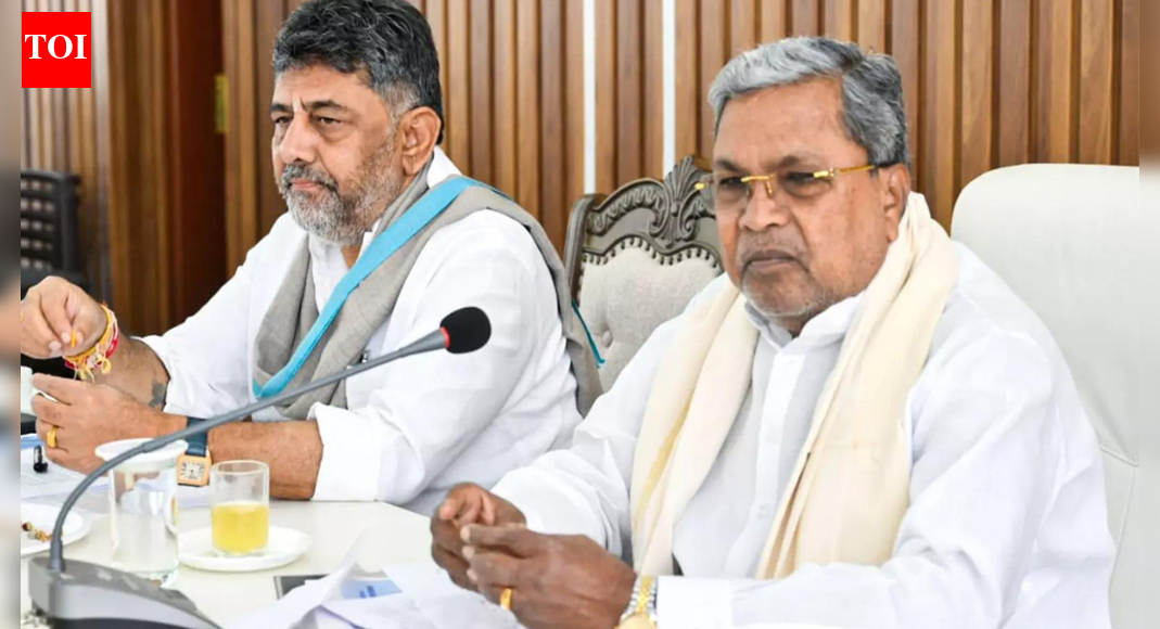 NEW DELHI: Karnataka deputy chief minister DK Shivakumar on Friday said that he will travel to Delhi to meet the high command over the “power tussle” between him and Siddaramaiah regarding the chief ministerial post.DKS said that he, along with chief minister Siddaramaiah, will travel to Delhi and the high command will make a decision over the anticipated reshuffle of the government.“I will definitely go to Delhi. It is our temple. Congress has a long history, and Delhi will always guide us. When they call me, party leaders and the CM, we will go there,” Shivakumar said.“My community is the Congress. I may belong to one community, and they may like it, but my love is for all sections of society… I don’t want anything; my party will make the decision,” he added.This comes as speculations over a change of guard in Karnataka grew as soon as the Congress government completed its halfway mark on November 20. Reports quoting Congress sources suggested that MLAs and MLCs from Shivakumar’s faction had camped in Delhi to push the party high command to make him the next chief minister.DK Shivakumar added to the speculations after he claimed that there had indeed been “a confidential understanding on leadership transition among five-six leaders” soon after Congress won a landslide in the 2023 elections.The deputy chief minister made the first reference to the power pact but stopped short of divulging more details. “This is confidential. I don’t want to speak publicly on this,” he said.However, the Congress chief played down the “internal conflict” within the party and said that the “high command” will sit together and deliberate on the issue.“Only the people there can say what the government is doing. But I would like to say that we will resolve such issues,” Kharge had said.“People in the high command — Rahul Gandhi, Sonia Gandhi and I — will sit together and deliberate on this… We will give the medicine when required,” he added.This was the first acknowledgment by Kharge that there is indeed a power struggle between Siddaramaiah and his deputy DK Shivakumar in Karnataka.Meanwhile, Karnataka minister Priyank Kharge also said that the Congress high command possesses the sense of timing to resolve the intensifying “power tussle” between chief minister Siddaramaiah and his deputy DK Shivakumar.Speaking to reporters, the minister said Siddaramaiah and Shivakumar have agreed to travel to Delhi for a meeting when summoned by the party high command.“Nobody has given any official invitation or statement on the meeting in New Delhi. The CM and the deputy CM have said that they will go to Delhi if they are invited by the Congress president or AICC general secretary and Karnataka in charge Randeep Singh Surjewala. Let the invitation come from Delhi, then only it will be decided,” Kharge, who is Congress president Mallikarjun Kharge’s son, said.Asked about the increasing confusion, Kharge said, “The high command has the sense of timing. It will take a call, keeping in mind the right time.” He urged people not to speculate further and said the high command will intervene whenever necessary.As the Congress government in Karnataka completed the halfway mark of its five-year tenure on November 20, the power tussle within the party has intensified over a possible change of guard in the state, with a section claiming an alleged “power-sharing” agreement between Siddaramaiah and Shivakumar in 2023.About the AuthorTOI News DeskThe TOI News Desk comprises a dedicated and tireless team of journalists who operate around the clock to deliver the most current and comprehensive news and updates to the readers of The Times of India worldwide. With an unwavering commitment to excellence in journalism, our team is at the forefront of gathering, verifying, and presenting breaking news, in-depth analysis, and insightful reports on a wide range of topics. The TOI News Desk is your trusted source for staying informed and connected to the ever-evolving global landscape, ensuring that our readers are equipped with the latest developments that matter most.”Read MoreEnd of ArticleFollow Us On Social MediaVideosGoldy Dhillon Gang Member Arrested In Delhi For Kapil Sharma’s Kap’s Cafe Shootings Across CanadaIndia Sends A Strong Warning: Rajnath Singh Says Sovereignty And Security Will Never Be NegotiableCongress, BJP Face Off Over Kumar Ketkar’s Controversial Remark CIA, Mossad Helped Modi Win in 2014Tejas Is The Safest, Says HAL Chief, Rejecting All Concerns After Dramatic Dubai Air Show AccidentPakistan Army General Warns Of Hybrid-To-Full War As Pakistan Reshapes Military Power Under MunirPakistan Erupts As Imran Khan’s Son Claims ‘No Proof Of Life’ Amid CM Afridi’s Jail-Side Protest’Darkest Times’: Imran Khan’s Sister Calls Out Pakistan Govt, Compares Asim Munir To Adolf HitlerIndia Must Prepare For Violent Future As CDS Chauhan Says Even One Failure Could Prove CatastrophicIndia Is a Key Ally, Cyprus Assures Strong Push to Finalise India–EU FTA TalksImran Khan Health Rumour: PTI Holds Sit In Outside Adiala Jail, KP CM Sohail Afridi Stages Protest123PhotostoriesBengaluru’s New AC Buses on NICE Road May Outrun Namma Metro on E-City–Madavara Stretch5 things not to do when buying clothes for your kidsAre you taking your supplements wrong? Common supplement mistakes that everyone is making (and how to avoid them)Your soul temple: 6 powerful temples to visit in India based on personality typesLike ‘Stranger Things’? ‘Karthikeya’, ‘Ekkadiki Pothavu Chinnavada’, ‘Awe!’, here are other Telugu films to watchHyderabad’s Skyroot Unveils Vikram-1: India’s First Private Orbital Rocket Ready for LaunchJennifer Lawrence’s parenting lessons that can teach modern moms how to raise kids without losing themselvesYour Enemy Planet According To Your Date of BirthThis Dharmendra record has stayed unchallenged for 50 Years- Even Shah Rukh Khan, Salman Khan, Amitabh Bachchan and Rajinikanth haven’t matched it7 foods that should never be given to dogs123Hot PicksDelhi AQI TodayNew Labour CodeWorld NewsGold rate todaySilver rate todayPublic Holidays NovemberBank Holidays NovemberTop TrendingJayden Daniels InjuryCyclone Ditwah ImpactBengaluru techieFortnite Chapter 7 LeakedAyesha CurryFuzzy ZoellerDelhi Car Blast10 Greatest Thanksgiving Moments in NFL historyGabrielle UnionVanessa Bryant