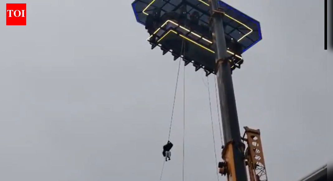NEW DELHI: Several tourists were left suspended nearly 120 feet above ground at a private sky-dining facility in Kerala’s Anachal, Idukki, after a crane suffered a technical failure on Friday. The visitors remained stuck for over one and a half hours.Rescue teams arrived at the site and efforts to bring them down safely are under way.The incident occurred near Munnar where a crane-operated dining platform, part of an adventure tourism initiative, had been offering visitors an aerial dining experience. The system, introduced only a few months ago, allows up to 16 people to be seated at a time, lifting them high above the valley for about half an hour while they dine with panoramic views.According to local reports the platform could not be lowered due to a mechanical fault believed to be related to the crane’s fuse. Fire and security personnel deployed from Munnar are currently working on alternative methods, including lowering individuals using ropes. Rescue operations are continuing as engineers attempt to restore the system and bring all stranded tourists and staff back to ground level.About the AuthorTOI News DeskThe TOI News Desk comprises a dedicated and tireless team of journalists who operate around the clock to deliver the most current and comprehensive news and updates to the readers of The Times of India worldwide. With an unwavering commitment to excellence in journalism, our team is at the forefront of gathering, verifying, and presenting breaking news, in-depth analysis, and insightful reports on a wide range of topics. The TOI News Desk is your trusted source for staying informed and connected to the ever-evolving global landscape, ensuring that our readers are equipped with the latest developments that matter most.”Read MoreEnd of ArticleFollow Us On Social MediaVideosViral Video: Stage Crashes During UP Wedding As BJP Leaders Gather To Greet Bride & GroomIndia-Russia Summit Dates Out As PM Modi, Putin Review S-400, Su-57 And Global Security ChallengesGoldy Dhillon Gang Member Arrested In Delhi For Kapil Sharma’s Kap’s Cafe Shootings Across CanadaIndia Sends A Strong Warning: Rajnath Singh Says Sovereignty And Security Will Never Be NegotiableCongress, BJP Face Off Over Kumar Ketkar’s Controversial Remark CIA, Mossad Helped Modi Win in 2014Tejas Is The Safest, Says HAL Chief, Rejecting All Concerns After Dramatic Dubai Air Show AccidentPakistan Army General Warns Of Hybrid-To-Full War As Pakistan Reshapes Military Power Under MunirPakistan Erupts As Imran Khan’s Son Claims ‘No Proof Of Life’ Amid CM Afridi’s Jail-Side Protest’Darkest Times’: Imran Khan’s Sister Calls Out Pakistan Govt, Compares Asim Munir To Adolf HitlerIndia Must Prepare For Violent Future As CDS Chauhan Says Even One Failure Could Prove Catastrophic123PhotostoriesSaturday Remedies: 5 Powerful Remedies To Appease Shani Dev10 phrases that can affect a child’s mood and mental health‘Tere Ishq Mei’ promotions: Turn up the sass this shaadi season with Kriti Sanon’s ‘Mukti’-inspired traditional looksKonkona Sen Sharma radiates timeless grace and powerful screen presenceBest fruit for liver health? This everyday fruit on an empty stomach can work wondersChennai’s New Mega Curve Over Kathipara Set to Redefine Metro Ride on Phase II CorridorMercury: Exploring the Solar System’s innermost planet; 7 fascinating facts!Bengaluru’s New AC Buses on NICE Road May Outrun Namma Metro on E-City–Madavara Stretch5 things not to do when buying clothes for your kidsIn Pics | Noida Airport Set for December 15 Inauguration123Hot PicksDelhi AQI TodayNew Labour CodeWorld NewsGold rate todaySilver rate todayPublic Holidays NovemberBank Holidays NovemberTop TrendingJayden Daniels InjuryCyclone Ditwah ImpactBengaluru techieFortnite Chapter 7 LeakedAyesha CurryFuzzy ZoellerDelhi Car Blast10 Greatest Thanksgiving Moments in NFL historyGabrielle UnionVanessa Bryant