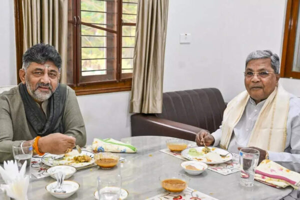 In an apparent display of unity, Karnataka Chief Minister Siddaramaiah is scheduled to visit his deputy D K Shivakumar’s residence for breakfast on December 2, just days after the two broke bread in the wake of a raging power tussle. This meeting, a follow-up to a similar one convened by the Congress high command.  NEW DELHI: Just as the Congress government in Karnataka crossed the halfway mark of its five-year term on November 20, chief minister Siddaramaiah and Deputy CM D K Shivakumar are making a renewed show of unity amid an escalating leadership tussle.Siddaramaiah on Tuesday visited Shivakumar’s residence for breakfast 2.0, a gesture seen as an attempt to ease tensions just days after the two leaders held a similar meeting at the chief minister’s home. Shivakumar on Monday extended an invitation to the CM to join him for breakfast, and posted on X saying, “Me and the CM continue to work together as a team. I have invited the Hon’ble CM for breakfast tomorrow to discuss and strengthen our collective efforts to deliver on our promises to Karnataka.”His comments came after Siddaramaiah told reporters “that day (Saturday) he (Shivakumar) asked me to come to his house for breakfast on Tuesday. I have not received any call till now. If invited, I will go. He may call. I think he will invite me.”Duo holds similar breakfast meeting The outreach is part of efforts to break the leadership deadlock between the two. Just two days earlier, Shivakumar had visited the CM’s residence for a similar breakfast meeting, called by Siddaramaiah on the high command’s instructions to ease tensions and present a united front ahead of the Belagavi legislature session beginning December 8.At a closely watched joint press briefing, Siddaramaiah and Shivakumar dismissed reports of a rift as “manufactured confusion” and agreed to remain united until the high command takes up the issue.Following the meet, Siddaramaiah said the talks had gone well. “Breakfast was very good. All three of us ( CM, deputy CM and advisor) enjoyed it,” he said. “We want to put an end to the confusion. Our mission is very clear — local elections are very important, and for the 2028 elections we are ensuring that Congress comes back to power. There is no difference between me and DKS — not now, not before.”He added “The media has created this confusion. From tomorrow, let there be no confusion.” He reiterated that both leaders would abide by the direction of the Congress high command, saying, “What the high command says, we will listen to and abide by.” Siddaramaiah added that the Assembly session beginning December 8 would be conducted smoothly and that the party would “fight BJP and JD(S) together.”Shivakumar, echoed the same stating that, “People have shown great trust and given a massive mandate to us. It is our duty to deliver to the people of Karnataka… Both of us have full trust in our leadership. One word from the high command, if they tell me to wait, I will wait. Both of us will follow whatever the high command says.” He added, “Whatever the CM says, I agree with him. We will not allow outsiders to interfere.” The show of unity comes amid intense speculation over a possible leadership change when the government completed half of its term. Rumours were fuelled by talk of a 2023 “power-sharing” understanding under which Siddaramaiah would serve 2.5 years and Shivakumar would lead the remaining tenure, a deal neither leader has openly acknowledged, and which the party has never confirmed.While Siddaramaiah maintains he will complete the full five-year term, Shivakumar’s camp has pushed for the alleged rotational formula. The high command is now working to keep both leaders aligned to avoid instability in the state.About the AuthorTOI News DeskThe TOI News Desk comprises a dedicated and tireless team of journalists who operate around the clock to deliver the most current and comprehensive news and updates to the readers of The Times of India worldwide. With an unwavering commitment to excellence in journalism, our team is at the forefront of gathering, verifying, and presenting breaking news, in-depth analysis, and insightful reports on a wide range of topics. The TOI News Desk is your trusted source for staying informed and connected to the ever-evolving global landscape, ensuring that our readers are equipped with the latest developments that matter most.”Read MoreEnd of ArticleFollow Us On Social MediaVideosIndia Stands Strong with B Russia Energy Investment, Ex-Envoy Malhotra ConfirmsWatch: MPs Speak Out as SIR Row Dominates Winter Session OpeningIndia’s Elections Earn Global Praise, CEC Calls It A ‘Moment Of Pride’ Amid Vote Row ClaimsHaryana Bodybuilder Killed After Standing Up To Harassers; Family Says Attack Was Planned MurderModi Trolls Opposition Over Bihar Setback Days Before Parliament ShowdownWoman Marries Boyfriend’s Corpse After Family Kills Him, Alleges Police Provoked BrotherMajor Twist In BrahMos Espionage Case As Higher Court Acquits Scientist Of Passing Defence SecretsRamaphosa Praises PM Modi’s Endorsement of South Africa Hosting G20 Summit, Counters Trump’s Claims‘Is There Any Law?’ Renuka Chaudhary Sparks Row After Bringing Stray Dog to ParliamentBSF IG Warns Of Looming Threat As 120 Terrorists Wait In PoK Despite Dip In Infiltration Attempts123PhotostoriesBaby names for girls born on Tuesday9 Hanuman Mantras According To Your Date of BirthSunny Deol, Jaya Bachchan to Kalki Koechlin: Bollywood actors who stepped behind the camera as scriptwritersDiabetes management: Doctor shares top 5 lifestyle strategies to lower HbA1c levelsFrom Sunda Pangolins to Sunda tiger: 5 of the most endangered animals in the world5 statement watches for women that will complete your traditional wedding lookKamal Haasan performances that redefined Indian cinema foreverIncrease protein intake: 4 easy ways to add more of it to everyday diet3 powerful anti-inflammatory drinks and how to make them at homeFrom Dead Sea Scrolls to Hope Diamond, 7 priceless objects in the world123Hot PicksParliament Winter SessionCyclone DitwahWorld NewsGold rate todaySilver rate todayPublic Holidays NovemberBank Holidays NovemberTop TrendingCardi BShedeur SandersDrake MayePat McAfeeCandace Owens Net WorthGisele BndchenConnor McDavidLian BichselLane Kiffin DaughterAnthony Davis