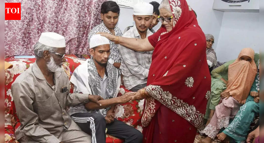 The sole survivor of a Saudi bus accident, Mohammed Abdul Shoaib, recounted how a tanker struck their vehicle, causing it to erupt in flames and kill 45 passengers, including his family. He escaped through a window as the bus caught fire, but his clothes ignited. Shoaib, now without support, has appealed to the Telangana government for a job. Mohammed Abdul Shoaib (centre), the lone survivor of the bus accident in Saudi Arabia’s Madina, with his family at his residence, in Hyderabad. (Picture credit: PTI) NEW DELHI: The only survivor of the November 17 Umrah bus accident in Saudi Arabia returned to India on Tuesday and described the moments before the vehicle went up in flames, killing 45 other passengers. Mohammed Abdul Shoaib said the bus was travelling towards Madinah when a passenger asked the driver to stop for a toilet break. “As the driver stopped the bus, it was struck from behind by a tanker,” he said, as per ANI.Shoaib recalled that the driver escaped through a window immediately after the crash and “didn’t try to help any of the passengers”. As the fire spread rapidly, Shoaib managed to climb out of the same window, but his clothes had already caught fire. “There were 46 passengers on the bus, including me. Everyone else died,” he said, adding that his father, mother and maternal grandfather were among the victims.“I have no support left now. That is why I request the Telangana government to give me a government job,” he appealed.The group was part of a 54-member team that had flown from Hyderabad on November 9. Eighteen members of one extended family were among the dead. Shoaib survived only because he was seated beside the driver when the bus collided with the fuel tanker and burst into flames around 1.30 am.His brother, Mohammed Sameer, had said that he survived only because a visa delay kept him from travelling with the rest of the family. Sameer, who later reached Saudi Arabia and spoke to his injured brother in hospital, said Shoaib had “seen our parents being charred to death right in front of him”.The Telangana government has announced Rs 5 lakh ex gratia for the families of the dead and will send a team led by Minorities Welfare Minister Mohammed Azharuddin to coordinate relief.Saudi authorities have begun investigating the crash, which happened about 25 km short of the group’s destination.About the AuthorTOI News DeskThe TOI News Desk comprises a dedicated and tireless team of journalists who operate around the clock to deliver the most current and comprehensive news and updates to the readers of The Times of India worldwide. With an unwavering commitment to excellence in journalism, our team is at the forefront of gathering, verifying, and presenting breaking news, in-depth analysis, and insightful reports on a wide range of topics. The TOI News Desk is your trusted source for staying informed and connected to the ever-evolving global landscape, ensuring that our readers are equipped with the latest developments that matter most.”Read MoreEnd of ArticleFollow Us On Social MediaVideosNavy Chief Confirms India’S Third Nuclear-Powered Ballistic Missile Submarine Soon“Both ‘Rs Must Remember Responsibility”: Bjp Slams Rahul, Renuka Over ‘Dog’ RemarksNo More Disruptions: Lok Sabha to Debate Electoral Reforms Next Week’Imran Khan’s Health Stable, But Facing Mental Torture’, Claims Sister After Jail VisitChina’s Condom Tax Shocks the World Amid Birthrate Drop as India Surges Ahead in Population RankingsPakistan Sparks Controversy With Expired Relief Claims As India Rejects Airspace Allegation StronglyCentre Signals Willingness to Discuss SIR, Asks Opposition Not to Set TimelinePakistan’s Adiala Jail To Open Gate To Imran Khan’s Sister After PTI Fury Forces Sharif, MunirRussia Confirms Su-57 Fighter Jets, S-400 Deal On Agenda Ahead of Vladimir Putin’s India VisitCapt Shubhanshu Shares What India Can Learn from ISS Successes123Photostories5 timeless quotes by Rumi that echo the true essenceof loveNature’s smartest travellers: 5 animals with homes on their backsFrom Cinnamon Tea to Methi Shots: 8 foods and drinks with proven heart benefitsShah Rukh Khan, Amitabh Bachchan, Rajinikanth: Actors who played both hero and villain in the same film9 lesser-known Biryanis from different parts of IndiaVictoria and David Beckham: Parenting secrets from one of the strongest celebrity couples5 shocking signs the ‘Universe’ is trying to send you a message (Don’t Ignore number 3!)6 best foods for kidneys as per top gastroenterologistAhaan Panday to Vicky Kaushal: 5-star-approved looks that are stealing today’s spotlight5 things people with powerful intuition do without realising it123Hot PicksParliament Winter SessionCyclone DitwahWorld NewsGold rate todaySilver rate todayPublic Holidays NovemberBank Holidays NovemberTop TrendingCardi BIPL AuctionShedeur SandersDrake MayeGold Price PredictionImran Khan ProtestWWE Raw HighlightsIND vs SA 2nd ODI TimeTom BradySmriti Mandhana