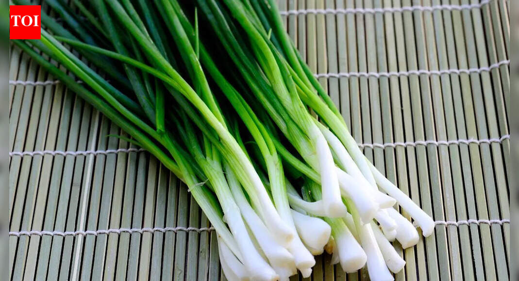 STOP throwing away slimy spring onions: A simple water trick keeps them fresh and crisp for weeks |