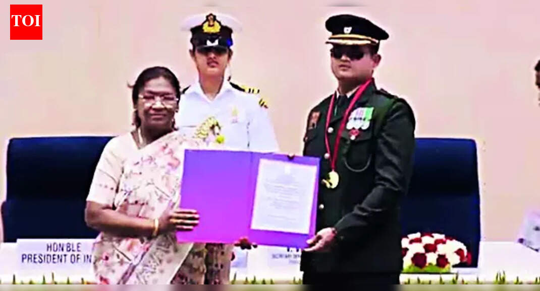 President Droupadi Murmu presents Lt Col C Dwarakesh with the National Award for Persons with Disabilities on Wednesday PUNE: A basketball match at a military station in 2014 was one of the last things Lt Col C Dwarakesh saw before an accident left him blind. He would spend the next eight months in hospital, healing and adjusting to life without eyesight while his mind envisioned new possibilities.On Wednesday, President Droupadi Murmu presented the 36-year-old with the National Award for Persons with Disabilities, recognising an Army career that even disability couldn’t cut short, and one that now includes a world record in para shooting.Lt Col Dwarakesh is the first officer of the Indian armed forces to continue in active service despite total blindness. It’s an achievement made possible by the derring-do of a young officer who never gave up on himself despite no precedent.“As an Army officer, I was trained to have conviction, courage, willpower and tenacity. But blindness is an impediment I couldn’t have prepared for,” Lt Col Dwarakesh told TOI from Delhi. “I overcame this hurdle through academics and technology, clearing multiple competitive exams along the way. I now research para sports, especially for people living with blindness. I converted my disability into a power and found ways to express the way those with vision do. This mindset has helped me reach new heights.”Supported by AI tools and assistive technology, Dwarakesh performs his responsibilities with the same proficiency and precision as his colleagues. In paralympic sports, he is a national champion in swimming and shooting, ranked world No. 3 in the 10m air rifle event. His most recent achievement was a world record score of 624.6 at the Shooting World Cup in the UAE this Oct. As part of the Indian para shooting team, he trains at Army Marksmanship Unit in Mahou.Dwarakesh, who joined the Army in 2009, terms the national award a “full-circle moment”. “I remember being granted commission by the President,” he said. “And to be receiving an award from the President 16 years later for something that redefined me, that’s quite something.”The officer, a native of TN, has also qualified for the UGC NET, making him one of the few visually impaired academicians in management, human resources, labour law, and sports research.End of ArticleFollow Us On Social MediaVideos”Derogatory” BJP Hits Out at Revanth Reddy Over Remarks On Hindu DeitiesOver 70 IndiGo Flights Cancelled Across India as Crew Shortage Triggers Massive Disruption“India’s Diplomacy Has Spine”: Tharoor Praises India’s Assertive Foreign Policy On RussiaRahul–Priyanka Candid Chat Goes Viral As Camera Catches Fun Banter’We Have A Diplomatic Allergy’: Shashi Tharoor Warns India Still Lacks A National Security StrategySanchar Saathi App Row In LS: Cong Flags Privacy Fears, Scindia Says ‘Snooping Not Possible’Rupee Slides To Record Low Of 90 Per Dollar As Trade Uncertainty, Dollar Demand And Oil Costs Spike’Leader Is Bulldozing’: Kharge, Nadda Lock Horns Over TMC MP’s Speech In Rajya SabhaIndia’s Workforce Power Will Keep Growing, Jaishankar Says, As He Takes Down Anti H-1B NarrativesKTR Slams Congress, Says Rahul Gandhi Has No Vision And Is An Albatross Around Opposition’s Neck123Photostories’Dhurandhar’: Times when the Ranveer Singh starrer made headlines6 most unique and expensive celebrity engagement rings that made historyThought of the day for your kid: “Don’t let what you can’t do stop you from what you can do.”Mammootty, Malayalam cinema and Bheeshma Parvam; Iconic roles ranked from cult classics to crowd favouritesProsenjit Chatterjee rising in Bollywood with intense and unforgettable characters10 best foods to boost muscle growth and strengthSay these 5 nighttime affirmations and watch your life transform in just days5 brutally honest lessons to take from Virat Kohli on how to crush successMalaika Arora’s yoga secrets: 5 beginner-friendly poses for body & mindHow Bhagavad Gita can heal unknown childhood trauma and unlock blockages for success in life123Hot PicksParliament Winter SessionPutin India VisitWorld NewsGold rate todaySilver rate todayPublic Holidays NovemberBank Holidays NovemberTop TrendingNBA Trade RumorsMike TysonWendy OrtizCardi BAuston MatthewsStephen CurryNathan MacKinnonJayden DanielsSuper Bowl LX Halftime ShowMolly Qerim