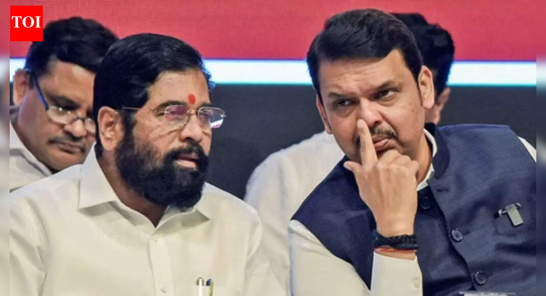 At a project unveiling in Dombivli, Maharashtra BJP chief Ravindra Chavan stood alongside Deputy Chief Minister Eknath Shinde and Kalyan MP Shrikant Shinde, signaling a possible reconciliation amidst rising tensions between the BJP and Shiv Sena regarding political maneuvering and activist recruitment, especially with local elections approaching. Chavan noted the enhanced collaboration within the ruling coalition. Maharashtra CM Devendra Fadnavis with his deputy Eknath Shinde (File photo) THANE: After weeks of escalating tensions between BJP and Shiv Sena in the Kalyan LS constituency over poaching of each other’s activists, Maharashtra BJP chief Ravindra Chavan shared stage with Dy CM Eknath Shinde and Kalyan MP Shrikant Shinde at the bhoomipujan of a Rs 180-crore multi-purpose sports complex, war memorial and several other projects in Dombivli.Their coming together signalled a possible pause in the ongoing conflict ahead of local body polls, where Sena has accused Chavan of poaching its workers. Chavan had also said accusations during elections were natural but stressed that BJP, Shiv Sena, and NCP had been functioning well together for the past year. — Pradeep Gupta ‘Maligning Hindu Way Of Life’: PM Modi Calls Out Colonial Mindset Over ‘Hindu Rate Of Growth’ Label End of ArticleFollow Us On Social MediaVideos’Maligning Hindu Way Of Life’: PM Modi Calls Out Colonial Mindset Over ‘Hindu Rate Of Growth’ LabelUP CM Yogi Slams Parties ‘Insulting Babasaheb’s Legacy’, Announces Security For Ambedkar Statues’Engaging Atmosphere Reigned’: Shashi Tharoor After State Dinner With Russian President Putin’Sab Jagah Pohchenge’: Yogi Adityanath On What’s Next After Ram Temple, ‘Kashi-Mathura’ Slogan’Black Day’: Owaisi Targets Modi Govt, Questions Acquittals In Babri Masjid Demolition CasePutin Dinner Snub Triggers War of Word: Priyanka Chaturvedi Slams ‘Petty’ Politics, BJP Blasts RahulHow Russia May Open Central Asia For India As West Pushes Harder: Kugelman Explains The Power ShiftAviation Meltdown Escalates As IndiGo Cancels 400 Flights And Government Enforces Fare ControlsUS Singer Calls PM Modi World’s Top Leader, Warns Washington To Recalibrate Its India Strategy FastEx-Pentagon Official Says Asim Munir Must Be Arrested As He Slams US Policy, Calls For India Apology123Photostories4 vitamins that boost brain power, foods rich in them, and a super easy multivitamin drink recipe5 snakes so beautiful that you won’t be able to look awayNutrition fact of the day: Green tea boosts metabolism and helps burn fat more efficientlyIn pics: Sourav Joshi and Avantika Bhatt’s simple Pahadi wedding fashion is a hit!Thought of the day for your child: “You are capable of amazing things”7 fish that make your aquarium instantly InstagrammableJhol Momo to Paalak Methi Mattar ka Saag: 15 dishes Vladimir Putin was served on his India tripSara Khan marries Krish Pathak in both Hindu and Muslim rituals, drops new photos; says ‘Qubool Hai se Saat Phere tak’Stressed and stiff? 4 yoga moves for instant relief10 reminders every working mom who feels guilty needs to hear today123Hot PicksIndigo Flight DelayPutin India VisitWorld NewsGold rate todaySilver rate todayPublic Holidays NovemberBank Holidays NovemberTop TrendingGautam GambhirDelhi Airport AdvisoryIndigo Flight CancellationCandace OwensAryna Sabalenka Net WorthHow to get danny Phantom in FortniteTravis KelceJohn Cena FinalJEE Advanced Exam DateDDA RecruitmentExam Schedule