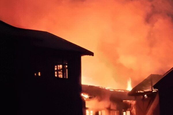 A devastating fire ripped through a North Goa nightclub, claiming at least 25 lives and injuring many more. The blaze, reportedly triggered by an explosion, occurred in an establishment operating without valid permissions. Fire safety norms were not followed, and access for emergency services was severely hampered, leading to a tragic loss of life. Goa nightclub fire (IANS photo) NEW DELHI: A weekend party night in North Goa turned into a tragedy after a massive fire tore through a nightclub in Arpora, killing at least 25 people and injuring many more late Saturday. Eyewitnesses said the blaze followed a “big fire” triggered by a “massive explosion,” in one of Goa’s busiest nightlife belts.Local authorities later confirmed that the club structure itself had no valid permissions. A panchayat official from Arpora said the establishment’s construction “was there without permission,” raising serious questions about regulatory oversight. Goa: 23 Killed In Arpora Nightclub Fire; Cylinder Blast Suspected, CM Sawant Vows Strict Action Several visitors described how close they came to being inside when the inferno erupted. Avanish from Delhi, who had planned to visit the restaurant, said, “…Actually, we got lucky because our cab driver was late or else we would be here…”A security guard at a nearby restaurant recalled the moment the blast shook the area: “…We heard a massive explosion. We later learned that the fire broke out after a cylinder blast…”Nikhnesh, also from Delhi, said he arrived just as smoke began rising. “As soon as we reached our hostel, we saw plumes of smoke rising… Actually, we were planning to come and party here last night… I think there was DJ party yesterday, I don’t know much about it.”Witnesses reported that between 100 and 150 people were on the dance floor when the fire broke out. In the panic, several people rushed downstairs into the kitchen area, where they were trapped along with staff members. Most of the victims, authorities said, were kitchen workers; among the dead were three women and several tourists.Sanjay Kumar Gupta, a security guard at Birch, said the tragedy unfolded within minutes. “The incident occurred between 11 pm and 12 am. Suddenly, there was a fire… I was at the gate… A DJ, dancer was going to come here, and it was about to get really crowded…”Fatima Shaikh, a tourist from Hyderabad, said the nightclub was packed for the weekend. “There was a sudden commotion as the flames started erupting… We rushed out of the club only to see that the entire structure was up in flames,” she said. Many who fled ran into the kitchen, not knowing it was a dead end. “They (tourists) got trapped there along with other staff… Many managed to run out of the club,” she added.The fire spread rapidly, aided by temporary décor made of palm leaves. Access for fire tenders was severely hindered: the club sits along the Arpora backwaters, reachable only through narrow lanes. Tankers had to be parked almost 400 metres away, slowing the response. A senior Fire and Emergency Services officer said the lack of access “made controlling the blaze a challenging task.” Most deaths occurred due to suffocation.Chief minister Pramod Sawant, who visited the site, said the club had not complied with fire safety norms. He announced an inquiry and assured strict action. “The nightclub had not followed the fire safety norms,” he said, adding that both the management and officials who allowed it to run would face consequences.Arpora-Nagoa panchayat sarpanch Roshan Redkar said the club was operated by Saurav Luthra, who was embroiled in a dispute with his partner. “We had inspected the premises and found that they did not have the permission to construct the club,” he said. A demolition notice had been issued earlier, but officials from the directorate of panchayats granted a stay.“The fire incident that happened was unfortunate… Now, we have to be more vigilant,” Redkar added.Calangute MLA Michael Lobo, who also reached the site, said all nightclubs in the area will face a fire safety audit starting Monday. He said notices would be issued seeking valid permissions, and “the licenses of clubs not having the necessary permissions will be cancelled.”About the AuthorTOI News DeskThe TOI News Desk comprises a dedicated and tireless team of journalists who operate around the clock to deliver the most current and comprehensive news and updates to the readers of The Times of India worldwide. With an unwavering commitment to excellence in journalism, our team is at the forefront of gathering, verifying, and presenting breaking news, in-depth analysis, and insightful reports on a wide range of topics. The TOI News Desk is your trusted source for staying informed and connected to the ever-evolving global landscape, ensuring that our readers are equipped with the latest developments that matter most.”Read MoreEnd of ArticleFollow Us On Social MediaVideosGoa: 23 Killed In Arpora Nightclub Fire; Cylinder Blast Suspected, CM Sawant Vows Strict Action’Maligning Hindu Way Of Life’: PM Modi Calls Out Colonial Mindset Over ‘Hindu Rate Of Growth’ LabelUP CM Yogi Slams Parties ‘Insulting Babasaheb’s Legacy’, Announces Security For Ambedkar Statues’Engaging Atmosphere Reigned’: Shashi Tharoor After State Dinner With Russian President Putin’Sab Jagah Pohchenge’: Yogi Adityanath On What’s Next After Ram Temple, ‘Kashi-Mathura’ Slogan’Black Day’: Owaisi Targets Modi Govt, Questions Acquittals In Babri Masjid Demolition CasePutin Dinner Snub Triggers War of Word: Priyanka Chaturvedi Slams ‘Petty’ Politics, BJP Blasts RahulHow Russia May Open Central Asia For India As West Pushes Harder: Kugelman Explains The Power ShiftAviation Meltdown Escalates As IndiGo Cancels 400 Flights And Government Enforces Fare ControlsUS Singer Calls PM Modi World’s Top Leader, Warns Washington To Recalibrate Its India Strategy Fast123PhotostoriesHow to know if your heart is healthy: Simple checks you can do at home5 sleep secrets that transform student performance: What science really saysPowerful mythological names for babies born on SundayYour soul purpose as per your birth month; goosebumps guaranteed!Explore the other wild South: Tamil Nadu’s 6 little-known wildlife sanctuaries to visit4 vitamins that boost brain power, foods rich in them, and a super easy multivitamin drink recipeNutrition fact of the day: Green tea boosts metabolism and helps burn fat more efficiently5 snakes so beautiful that you won’t be able to look awayIn pics: Sourav Joshi and Avantika Bhatt’s simple Pahadi wedding fashion is a hit!Thought of the day for your child: “You are capable of amazing things”123Hot PicksIndigo Flight DelayPutin India VisitWorld NewsGold rate todaySilver rate todayPublic Holidays NovemberBank Holidays NovemberTop TrendingGautam GambhirThe God Slayer Release DateRohit SharmaCandace OwensAryna Sabalenka Net WorthTim PoolAaron RodgersVirat KohliNarela Girl Sexually AssaultedBengaluru News