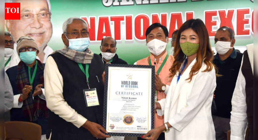 Bihar’s Chief Minister, Nitish Kumar, has received a prestigious accolade from the World Book of Records, London, acknowledging his exemplary political service and dedication to democracy. This achievement marks his historic tenth oath-taking as Chief Minister, a milestone that underscores both his resilience in governance and the confidence bestowed upon him by the citizens of Bihar. Photo credit: World Book of Records Bihar chief minister and JD(U) supremo Nitish Kumar has been officially recognised by the World Book of Records, London, for his “matchless contribution in politics” and for ‘strengthening democratic values’.Announcing the recognition on X on Friday, JD(U) national working president Sanjay Kumar Jha wrote “It is a matter of great joy and pride to share that the World Book of Records, London, has recognised the extraordinary milestone achieved by Hon’ble Chief Minister Shri @NitishKumar, who has taken oath as Chief Minister for the 10th time — a truly rare distinction in India’s democratic journey,”, adding that “The organisation’s commendation notes that this remarkable feat is a reflection of his unwavering public service, stable governance, and the enduring trust reposed in him by the people of Bihar. To lead a state across ten terms is not merely a personal achievement; it stands as a historic moment for Bihar and a testament to its democratic strength.The World Book of Records has also conveyed its intention to formally include Shri Nitish Kumar’s name in its distinguished global listings to honour this unmatched accomplishment.A proud moment for Bihar and a tribute to a leader whose steady commitment continues to guide the state’s progress.”  Six Ways Nitish Kumar Proved ‘Tiger Abhi Zinda Hai’ As NDA Registers Big Win in Bihar Assembly Polls WBR India adjudicators Sanjoy Dolo and Radha Richisow formally presented the certificate of honour to Nitish Kumar in a ceremony organised by Santosh Shukla, Supreme Court advocate and president of the World Book of Records.According to a WBR press release on Friday, “Shri Nitish Kumar, Hon’ble Chief Minister, Bihar (India) has been felicitated by World Book of Records, London for being Chief Minister of Bihar (India) for 04 terms with Matchless Contribution in Politics to Strengthen Democratic Values. The Certificate of Honour was presented to Shri Nitish Kumar (Hon’ble Chief Minister, Bihar) by Mr. Sanjoy Dolo (Adjudicator, WBR – India) and Ms. Radha Richisow (Adjudicator, WBR – India). This was informed by Shri Santosh Shukla, Supreme Court, Advocate (President, World Book of Records). On being recognized by World Book of Records, Shri Nitish Kumar was congratulated by Shri Virendra Sharma (Member of Parliament, England), Dr. Diwakar Sukul (Chairman, World Book of Records, London), Shri Santosh Shukla (President, World Book of Records) and other dignitaries from international scenario.”Nitish Kumar recently took the oath as Bihar chief minister for the 10th time after winning the Bihar assembly elections on November 20. Kumar has served over 19 years and three months in office since first assuming charge on March 3, 2000. His initial term lasted only seven days after failing to secure a majority, but he went on to become Bihar’s longest-serving chief minister, and known for the highest number of swearing‑in ceremonies (10 oaths) over a 25‑year span, a feat unmatched in Indian politics.About the AuthorTOI News DeskThe TOI News Desk comprises a dedicated and tireless team of journalists who operate around the clock to deliver the most current and comprehensive news and updates to the readers of The Times of India worldwide. With an unwavering commitment to excellence in journalism, our team is at the forefront of gathering, verifying, and presenting breaking news, in-depth analysis, and insightful reports on a wide range of topics. The TOI News Desk is your trusted source for staying informed and connected to the ever-evolving global landscape, ensuring that our readers are equipped with the latest developments that matter most.”Read MoreEnd of ArticleFollow Us On Social MediaVideos’I Regret That…’: Congress MP Shashi Tharoor On No Invite To Rahul, Kharge For Putin DinnerGoa: 23 Killed In Arpora Nightclub Fire; Cylinder Blast Suspected, CM Sawant Vows Strict Action’Maligning Hindu Way Of Life’: PM Modi Calls Out Colonial Mindset Over ‘Hindu Rate Of Growth’ LabelUP CM Yogi Slams Parties ‘Insulting Babasaheb’s Legacy’, Announces Security For Ambedkar Statues’Engaging Atmosphere Reigned’: Shashi Tharoor After State Dinner With Russian President Putin’Sab Jagah Pohchenge’: Yogi Adityanath On What’s Next After Ram Temple, ‘Kashi-Mathura’ Slogan’Black Day’: Owaisi Targets Modi Govt, Questions Acquittals In Babri Masjid Demolition CasePutin Dinner Snub Triggers War of Word: Priyanka Chaturvedi Slams ‘Petty’ Politics, BJP Blasts RahulHow Russia May Open Central Asia For India As West Pushes Harder: Kugelman Explains The Power ShiftAviation Meltdown Escalates As IndiGo Cancels 400 Flights And Government Enforces Fare Controls123PhotostoriesShort, modern and meaningful unisex baby namesKerala actress assault case: 8-year timeline of the trial; Dileep awaits verdict in historic courtroom battleHow to know if your heart is healthy: Simple checks you can do at home5 sleep secrets that transform student performance: What science really saysPowerful mythological names for babies born on SundayYour soul purpose as per your birth month; goosebumps guaranteed!Explore the other wild South: Tamil Nadu’s 6 little-known wildlife sanctuaries to visit4 vitamins that boost brain power, foods rich in them, and a super easy multivitamin drink recipe5 snakes so beautiful that you won’t be able to look awayNutrition fact of the day: Green tea boosts metabolism and helps burn fat more efficiently123Hot PicksIndigo Flight DelayPutin India VisitWorld NewsGold rate todaySilver rate todayPublic Holidays NovemberBank Holidays NovemberTop TrendingGautam GambhirThe God Slayer Release DateRohit SharmaCandace OwensAryna Sabalenka Net WorthTim PoolAaron RodgersVirat KohliNarela Girl Sexually AssaultedBengaluru News