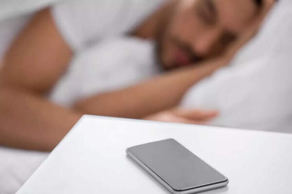Sleeping next to your phone may cause brain cancer, fertility issues, and other hidden health risks, experts warn about |