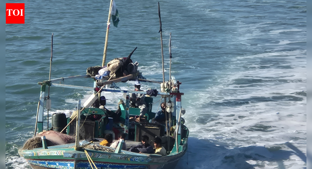 The Indian Coast Guard apprehended a Pakistani fishing boat with 11 crew members for illegally operating within Indian waters. This decisive action underscores India’s commitment to protecting its maritime frontiers and upholding international maritime law. The operation highlights the Coast Guard’s sustained vigilance and proactive approach to national maritime security. (Image credits: X @IndiaCoastGuard) NEW DELHI: Indian Coast Guard (ICG) on Wednesday seized a Pakistani fishing boat and apprehended 11 crew members for operating illegally in Indian waters, officials said. The detainees have been handed over to the Jakhau Marine Police in Gujarat for further investigation.ICG on Thursday confirmed the interception on X, stating that it had “intercepted and apprehended a Pakistani fishing vessel along with 11 crew operating illegally inside Indian waters. ” The force said the “decisive action reflects the unwavering vigilance of the ICG and India’s firm resolve to protect its maritime frontiers and uphold international maritime law within the MZI. Relentless surveillance and proactive operation remain the bedrock of our maritime security strategy.”Gujarat Defence PRO Wing Commander Abhishek Kumar Tiwari said the operation was carried out swiftly. In a post on X, he wrote that the Coast Guard had “apprehended a Pakistani fishing boat with 11 crew inside India’s Exclusive Economic Zone (EEZ).” He said the interdiction highlights the Coast Guard’s sustained maritime operations and India’s commitment to securing its frontiers while enforcing international laws within the Maritime Zones of India (MZI). “Continuous vigilance across India’s maritime domain remains a cornerstone of our national maritime security strategy,” he added.Last year, an ICG ship rescued seven Indian fishermen who had been apprehended by a Pakistan Maritime Security Agency (PMSA) vessel near the India-Pakistan maritime boundary. The ICG intercepted the Pakistani vessel Nusrat and chased it for nearly two hours before persuading it to release the fishermen on November 17.About the AuthorTOI News DeskThe TOI News Desk comprises a dedicated and tireless team of journalists who operate around the clock to deliver the most current and comprehensive news and updates to the readers of The Times of India worldwide. With an unwavering commitment to excellence in journalism, our team is at the forefront of gathering, verifying, and presenting breaking news, in-depth analysis, and insightful reports on a wide range of topics. The TOI News Desk is your trusted source for staying informed and connected to the ever-evolving global landscape, ensuring that our readers are equipped with the latest developments that matter most.”Read MoreEnd of ArticleFollow Us On Social MediaVideosTrump’s  Million Gold Card Explained: What America’s Costliest Visa Means For Indian ApplicantsUS Clears 6 Million F-16 Upgrade For Pakistan, Sparking Major Strategic Ripples Across South AsiaGoa Club Owners Saurabh & Gaurav Luthra Arrested in Phuket After Deadly Fire‘Damaging India, Hurting America’: Jayapal Flags Tariff Crisis Hitting Both NationsAmid Flight Meltdown, IndiGo Chairman Denies Claims of Rule Manipulation and Crisis EngineeringIndia-US Relations Face Hurdle As US Engages Pakistan Military, Says Dhruva JaishankarIndia Slams Pakistan At UN For Airstrikes And ‘Trade Terrorism’ That Deepen Afghanistan’s CrisisLawmaker Says Trump Damaged India–US Relations After Modi–Putin Selfie Sparks BacklashDonald Trump’s ‘Gold Card’ Promises New Path For Indians, US Allows Companies To Hire Top Graduates’PM Modi Hacks Hearts, Not EVM’: Kangana Ranaut Lambasts Rahul Gandhi During SIR Debate In Lok Sabha123Photostories8 everyday popular foreign brands Indians often assume are IndianBaby boy names inspired by Lord VishnuGoa club inferno chase: Luthra brothers nabbed in Thailand after deadly blaze sparks global manhuntFoods that must never be eaten rawLow-calorie alcohol options that don’t ruin your dietNine Famous Dohas By Kabir According To Your Date of Birth‘Tumbbad’, ‘Bulbbul’, ‘Munjya’: Step into a world of ancient beliefs and dark legends with these folklore-based moviesBhagavad Gita lesson for each birth month (powerful guide)Hindu Shloka Your Child Should Chant Based On Their Birth DateTop 10 most beautiful countries in the world as per 2025 rankings123Hot PicksParliament Winter SessionTrump Gold CardSpiceJet FlightGold rate todaySilver rate todayPublic Holidays NovemberBank Holidays NovemberTop TrendingSherrone MooreIsaiah RiderStephen CurryAdrian MorejonFerrari Carnage KolkataRomeo Lane FireMohan BhagwatBengaluru CrimePaige Shiver Net WorthGabrielle Union
