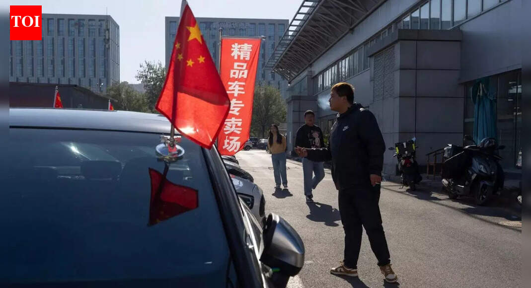 High-end car sales sink in China as its economy slows, taking a toll on European automakers