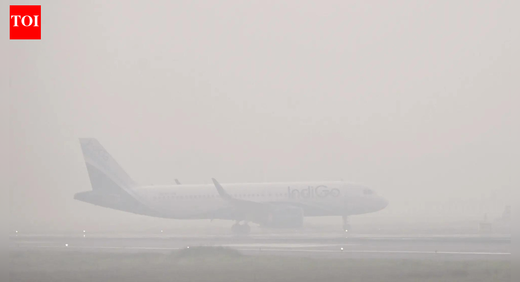 NEW DELHI: Delhi airport on Tuesday issued an advisory to flyers, warning that disruptions in flight operations may persist for some arrivals and departures due to dense fog.In a post on X, Indira Gandhi International Airport (IGIA) urged passengers to check with airlines for real-time updates on flight schedules.“Flight operations are steadily recovering, but disruptions may persist for certain departures and arrivals. For accurate and timely updates, please contact your airline directly,” IGIA said.“Our personnel are available across terminals to assist passengers and provide necessary support,” it added.Low visibility had disrupted operations on Monday as well, with 228 flights — 131 departures and 97 arrivals — cancelled and five diverted to nearby airports, according to airport officials.Air India said it cancelled around 40 flights due to poor visibility, while other airlines, including IndiGo, did not share exact numbers of cancellations or delays.“Low visibility (below minima), due to dense fog, has severely impacted operations at Delhi and other airports across northern India,” IndiGo said, adding that some flights may face delays or proactive cancellations to prioritise safety.Air India also said operations would resume as soon as conditions improve, stressing that cancellations were made in the interest of passenger safety.Delhi airport, the country’s busiest, handles around 1,300 flight movements daily.About the AuthorTOI News DeskThe TOI News Desk comprises a dedicated and tireless team of journalists who operate around the clock to deliver the most current and comprehensive news and updates to the readers of The Times of India worldwide. With an unwavering commitment to excellence in journalism, our team is at the forefront of gathering, verifying, and presenting breaking news, in-depth analysis, and insightful reports on a wide range of topics. The TOI News Desk is your trusted source for staying informed and connected to the ever-evolving global landscape, ensuring that our readers are equipped with the latest developments that matter most.”Read MoreEnd of ArticleFollow Us On Social MediaVideosIndian Army Displays Turkish Yiiha Drone Used By Pakistan During Operation SindoorPM Modi Arrives In Jordan, Receives Warm Welcome By Indian Diaspora In AmmanUS Starts Mandatory Social Media Checks For H-1B Visas Leaving Indian Professionals Most ExposedBJP’s Succession Script Repeats: Why Nitin Nabin Is Working President, And Not Nadda’s ReplacementEnd Of MGNREGA? What VB–G Ram G Means For Rural Workers, Farmers And Viksit Bharat PlanFrom Missiles To Torpedoes, DRDO Outlines India’s Big Defence Push For Near-Term Battlefield EdgePM Modi Begins Jordan, Ethiopia, Oman Tour To Boost Ancient Ties, Expand India’s Global South RoleIndian Diaspora Members Prepare Cultural Performances Ahead Of PM Modi’s Jordan VisitFrom Power Cuts To 500 GW Grid, India Emerges As Global Data Centre Hub Under Modi: Piyush GoyalCong’s ‘Modi Teri Kabr Khudegi’ Slogan Sparks Uproar, NDA Seeks Apology As Parliament Grinds To Halt123PhotostoriesFrom corpse flowers to blood grass: 7 plants that look supernatural but are realMrunal Thakur embraces her ‘Purna Marathi’ side in a timeless Paithani sareeFrom Chimpanzees to Rats: 5 animals who are smarter than you think!TV actors who married young: From Karanvir Bohra to Vivian DsenaLongest running Hindi TV shows: Taarak Mehta Kaa Ooltah Chasmah’ to ‘Balika Vadhu’Dear Comrade, Pelli Choopulu and Arjun Reddy; Breakthrough performances that redefined the Telugu lover boyDhurandhar, Chhaava, Mom; Challenging roles played by Akshaye Khanna5 adorable pink animals stealing the wildlife spotlight5 beautiful Romeo and Juliet quotes that will steal your hearts‘Damini’, ‘OMG! Oh My God’, ‘Prem Rog’: Bollywood movies that sparked social change and redefined mainstream storytelling123Hot Picksilia TopuriaCorona RemediesJetBlue flight VenezuelaGold rate todaySilver rate todayPublic Holidays NovemberBank Holidays NovemberTop TrendingJosh AllenAuston MatthewsVanessa BryantLeBron JamesBukayo Saka and Tolami Benson Net WorthConnor McDavidTomi LahrenAdolis GarciaDeante Ayton MomBrock McGillis
