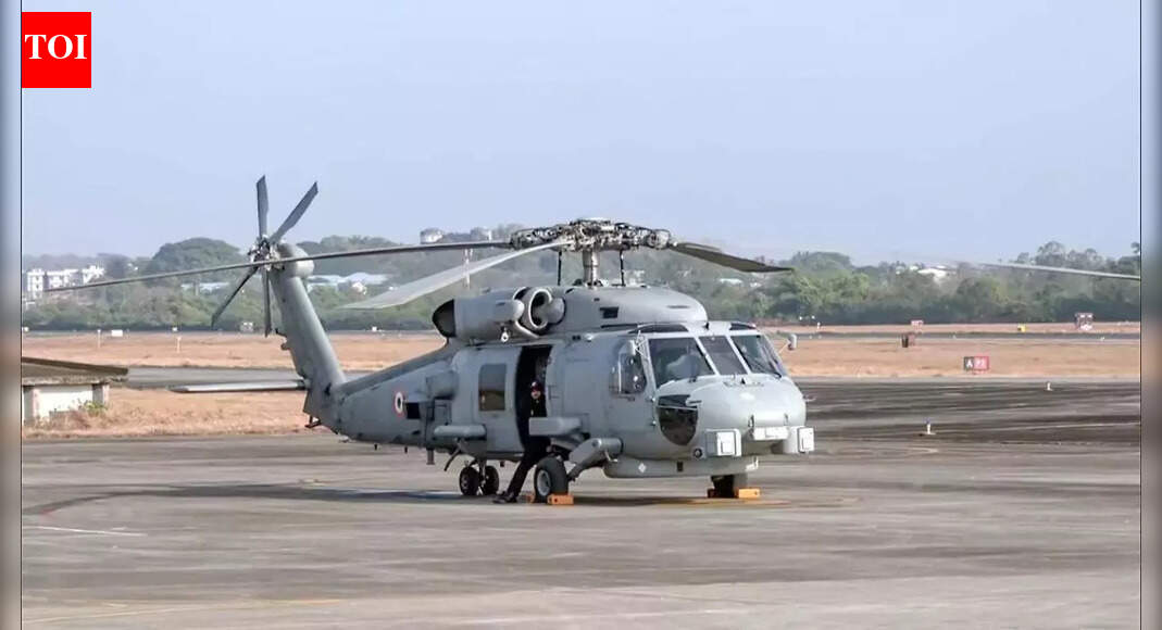 India’s Navy has boosted its submarine warfare and surveillance with the commissioning of its second MH-60R helicopter squadron, INAS 335, at Goa. This move strengthens maritime security amid a complex regional environment. The induction enhances the Navy’s operational reach and deterrence, aligning with India’s strategic goals for a secure maritime future. Indian Navy commissioned its second MH 60R helicopter squadron, INAS 335 (Ospreys) at INS Hansa, in Vasco on Wednesday. NEW DELHI: The Indian Navy on Wednesday commissioned its second squadron of MH-60R (Romeo) multi-role helicopters, INAS 335 ‘Ospreys’, at Goa’s INS Hansa naval air base, marking a key step in strengthening India’s submarine warfare and maritime surveillance capabilities on the western seaboard.The squadron was commissioned in the presence of Chief of Naval Staff Admiral Dinesh Tripathi, with the induction ceremony marked by a traditional water cannon salute. The event concluded with a march past of the newly inducted helicopters, often described as the Navy’s “flying destroyers”. India Strengthens Maritime Dominance As Second MH-60R Squadron Joins Indian Navy At INS Hansa Addressing the gathering, Admiral Tripathi shed light on the changing nature of threats in India’s maritime neighbourhood. “The maritime environment around us, today, is more complex and contested than ever before. Shifting geopolitics, fast-moving technologies, and an expanding spectrum of threats – from grey-zone activities to supply chain disruptions at sea – are shaping this new reality,” he said.He said the Navy’s modernisation drive is closely linked to India’s broader strategic goals. It is within this challenging and dynamic strategic context that India is undertaking its maritime voyage towards becoming Viksit Bharat by 2047, he added. Indian Navy’s second MH-60R squadron INAS 335 at INS Hansa “Strengthening maritime security and deterrence, therefore, are fundamental to safeguarding our sea lines of communications, and growing national maritime interests,” the Navy chief said.Highlighting the operational significance of the induction, Admiral Tripathi said the deployment of the MH-60R helicopters on the western coast as the first operational squadron marked a major milestone for naval aviation. “The induction of the versatile, multi-role MH60R helicopter on the Western Seaboard, as the first operational squadron, marks an important milestone for our Navy,” he said.The Navy chief also drew attention to the historical resonance of the occasion. “The commissioning today also comes at a moment of great significance – 2025 marked 75 years since the Government of India approved the formation of a Fleet Air Arm, a decision that gave wings to Naval Aviation, thereby transforming our Navy into a potent multi-dimensional force, and giving us a decisive edge at sea,” he said.He noted that the date also coincided with a key chapter in India’s military history. “It is a matter of even greater significance that, precisely 64 years ago, on the night of 17/18 Dec 1961, Operation Vijay commenced, wherein ships of the Indian Navy sailed into Goa, to liberate it from the Portuguese,” Admiral Tripathi said.Recalling the role of naval aviation during that operation, he added, “There too, Naval Aviation played a part, with the erstwhile Vikrant and its integral air wing stationed just beyond the horizon, securing the approaches to Goa.”Why does it matter?The Navy chief outlined how the MH-60R induction fits into a broader push to enhance maritime domain awareness and strike capability. He said the Navy is moving ahead with the acquisition of 15 MQ-9B Sea Guardian remotely piloted aircraft, which will bolster persistent surveillance across India’s maritime areas of interest.“In addition to building its shore-based aviation capabilities, the Indian Navy has maintained an unwavering focus on the enhancement of the integral shipborne aviation capabilities – both fixed and rotary wing,” he said.Admiral Tripathi said recent procurements were aimed at building a balanced and future-ready force. “It is in this context that the recent signing of the contract for 26 Rafale-M carrier-borne aircraft assumes particular significance, strengthening our long-range maritime strike and land-attack capabilities, as well as Fleet Air Defence,” he said.He added that rotary-wing platforms play a critical supporting role at sea. “Complementing the deck-based fighters, rotary-wing platforms, that include the shipborne Uncrewed Aviation Systems, extend the Fleet’s ability to undertake persistent surface and air surveillance, standoff anti-submarine and anti-surface warfare, logistics support, and search-and-rescue at sea,” he said.With the commissioning of INAS 335, the Navy’s operational footprint in the Arabian Sea is set to deepen, reinforcing India’s maritime deterrence posture at a time of intensifying strategic competition in the region.About the AuthorTOI News DeskThe TOI News Desk comprises a dedicated and tireless team of journalists who operate around the clock to deliver the most current and comprehensive news and updates to the readers of The Times of India worldwide. With an unwavering commitment to excellence in journalism, our team is at the forefront of gathering, verifying, and presenting breaking news, in-depth analysis, and insightful reports on a wide range of topics. The TOI News Desk is your trusted source for staying informed and connected to the ever-evolving global landscape, ensuring that our readers are equipped with the latest developments that matter most.”Read MoreEnd of ArticleFollow Us On Social MediaVideos‘Might Never See Him Again’: Imran Khan’s Sons Claim ‘Psychological Torture’ In Pak’s Adiala JailDelhi Pollution: China Shares Playbook On How To Fix Air Quality Amid Politics Over AccountabilityExplained: The ₹30 Crore Film Deal That Led To Bollywood Director Vikram Bhatt And His Wife’s ArrestIndia Strengthens Maritime Dominance As Second MH-60R Squadron Joins Indian Navy At INS HansaViksit Bharat Shiksha Adhishthan Bill Explained: Education Reform Or A Quiet Erosion Of FederalismNational Herald Case: Kharge Alleges ED Misuse, BJP Strikes Back With ‘Most Corrupt Family’ DigFrom Vande Mataram To Shared Roots: Highlights Of PM Modi’s Historic Speech In Ethiopian ParliamentVande Mataram Echoes In Ethiopia As Singers Honour PM Modi At Banquet Hosted By Abiy Ahmed‘Jhukta Wahi Hai…’: Abhishek Banerjee Cites Kumbh To Defend TMC On Messi Event ChaosPolitical Row Over Op Sindoor: Prithviraj Chavan Doubles Down on ‘Defeat’ Claim, BJP Blasts Congress123Photostories7 skin symptoms that may signal uncontrolled diabetesFrom Ghost Promotion to Career Shrekking: 5 trends in 2025 that are defining the future of workChef Sanjeev Kapoor’s warm and comforting veg soups for winter monthsKajol × Manish Malhotra: The fashion love story Bollywood still can’t move on fromPariksha Pe Charcha 2026: 6 thoughtful questions to ask PM Modi this yearChristmas in South India: 10 destinations that you shouldn’t miss out onHow to identify signs of depression in your childPost-partum depression: What every parent should know about it9 Reasons to consume Persimmon and how to make 2 ingredient viral Christmas no bake cake with the fruitInside the jewellery vaults of Indian royal families: Iconic head ornaments that owned the moment123Hot PicksBomb Threat AhmedabadPark Medi World sharesPunjab election result 2025Gold rate todaySilver rate todayPublic Holidays DecemberBank Holidays DecemberTop TrendingLuka DoncicStephen CurryMegan Thee StallionStephen Curry and Ayesha Curry RumorsConnor McDavid Luxury Car CollectionGoverment Job VacanciesBukayo Saka and Tolami Benson Net WorthSSN College AdmissionsFortnite Winterfest Release DateRussell Wilson Wife
