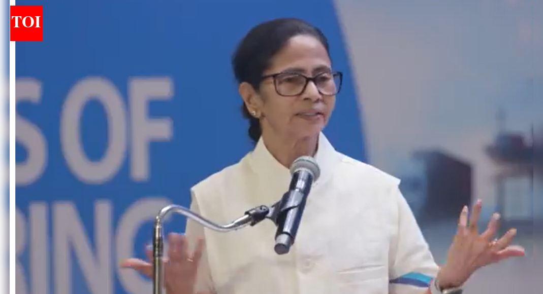 NEW DELHI: West Bengal chief minister Mamata Banerjee on Thursday announced that the state government’s job scheme ‘Karmashree’ will be renamed after Mahatma Gandhi, saying she felt “ashamed” that the Father of the Nation’s name was being removed from welfare scheme at the national level.Speaking at a public event, Banerjee said the scheme, which provides 75 to 100 days of employment, would be renamed to honour Mahatma Gandhi, asserting that the state would uphold the legacy of national leaders if the Centre fails to do so. End Of MGNREGA? What VB–G Ram G Means For Rural Workers, Farmers And Viksit Bharat Plan “We have started a scheme ‘Karmashree’, Gandhi ji name is not there. I’m really sorry, I’m ashamed. I’m feeling shame, father of the nation, MGNREGA program named after him, now the bill came Gandhi ji name won’t be there,” Banerjee said.She added, “I can’t blame anybody except me because I belong to this country. I’m feeling ashamed because we are even forgetting the father of the nation.”The CM said the scheme’s name would now be changed to reflect Mahatma Gandhi’s legacy. “So we have started a scheme called ‘Karmashree’, it’s name will be changed to Mahatma ji scheme. It will also give 75 to 100 days of job…we’re not beggars,” she said.Banerjee also took a swipe at the Centre, saying, “We only won’t respect nothing else, if you will not give respect to Mahatma ji we will.”In her address, Banerjee invoked several national leaders, what she described as Bengal’s inclusive ethos.“We know how to give respect to Mahatma ji, Neta Ji, Guru dev Rabindranath, Baba Sahaeb Ambedkar, Maulana Abul kalam, Sardar Patel, Lal Bal Pal, we love every community,” she said.The remarks come amid an ongoing political row over changes made to the name of MGNREGA, including the omission of Mahatma Gandhi’s name from official titles, which the TMC and other opposition parties have criticised.About the AuthorTOI News DeskThe TOI News Desk comprises a dedicated and tireless team of journalists who operate around the clock to deliver the most current and comprehensive news and updates to the readers of The Times of India worldwide. With an unwavering commitment to excellence in journalism, our team is at the forefront of gathering, verifying, and presenting breaking news, in-depth analysis, and insightful reports on a wide range of topics. The TOI News Desk is your trusted source for staying informed and connected to the ever-evolving global landscape, ensuring that our readers are equipped with the latest developments that matter most.”Read MoreEnd of ArticleFollow Us On Social MediaVideosLok Sabha Passes Viksit Bharat G Ram G Bill Amid Protests, Opposition Tears Copies Over Gandhi Name‘Worst Is Behind Us’: IndiGo CEO Says Airline Back on Track After Operational CrisisIndia Has Changed Its Economic DNA, Grows Over 8 Percent Amid Global Challenges: PM Modi in Oman’Roz Gandhi Ko Maarte Ho’: BJP MP Nishikant Dubey’s Fiery Speech Targets Cong, Triggers Chaos in LSFrom Work-From-Home To Vehicle Ban- Delhi Rolls Out Fresh Pollution CurbsSeagull With China-Made GPS Device Near Karnataka Naval Base Triggers Spy Buzz; Here’s the Truth’India Got Out Of The Gates Faster Than Most Nations’, Says US Expert As Trade Deal Talks Nears EndRise of Islamists In Bangladesh Sparks Alarm As Sheikh Hasina’s Son Warns India of Imminent Threat“SHANTI Is A Cruel irony”: Tharoor Tears Into Modi Govt Over Nuclear Bill’Vande Mataram’ Chants Echo As Indian Diaspora Welcomes PM Modi In Oman123PhotostoriesPrada’s Kolhapuri sandals to Louis Vuitton’s ‘Auto Bag’: 5 most controversial releases of 2025TV stars who got married in 2025: Hina Khan and Rocky Jaiswal to Sara Khan and Krish PathakCan eating kacchi haldi bring down iron levels?7 Behaviour traits children directly acquire from their mothersBollywood political portrayals from Thackeray, The Accidental Prime Minister, Sardar5 destinations that became popular unexpectedly7 signs you’re not drinking enough waterChennai transit upgrade stalled: Royapuram bus terminus built but remains non-operational7 Reasons why children love dad more than momNidhhi Agerwal, Allu Arjun, Deepika Padukone: 5 Times actors were mobbed by fans123Hot PicksTrump Gold CardUAE WeatherIndia Oman TradeGold rate todaySilver rate todayPublic Holidays DecemberBank Holidays DecemberTop TrendingKyrie IrvingBrian SmithSarfaraz KhanThe UndertakerPatrick Mahomes InjuryUGC Net Exam ScheduleRavi BishnoiNidhhi AgerwalStephen Curry NBA ContractNBA Cup Banner